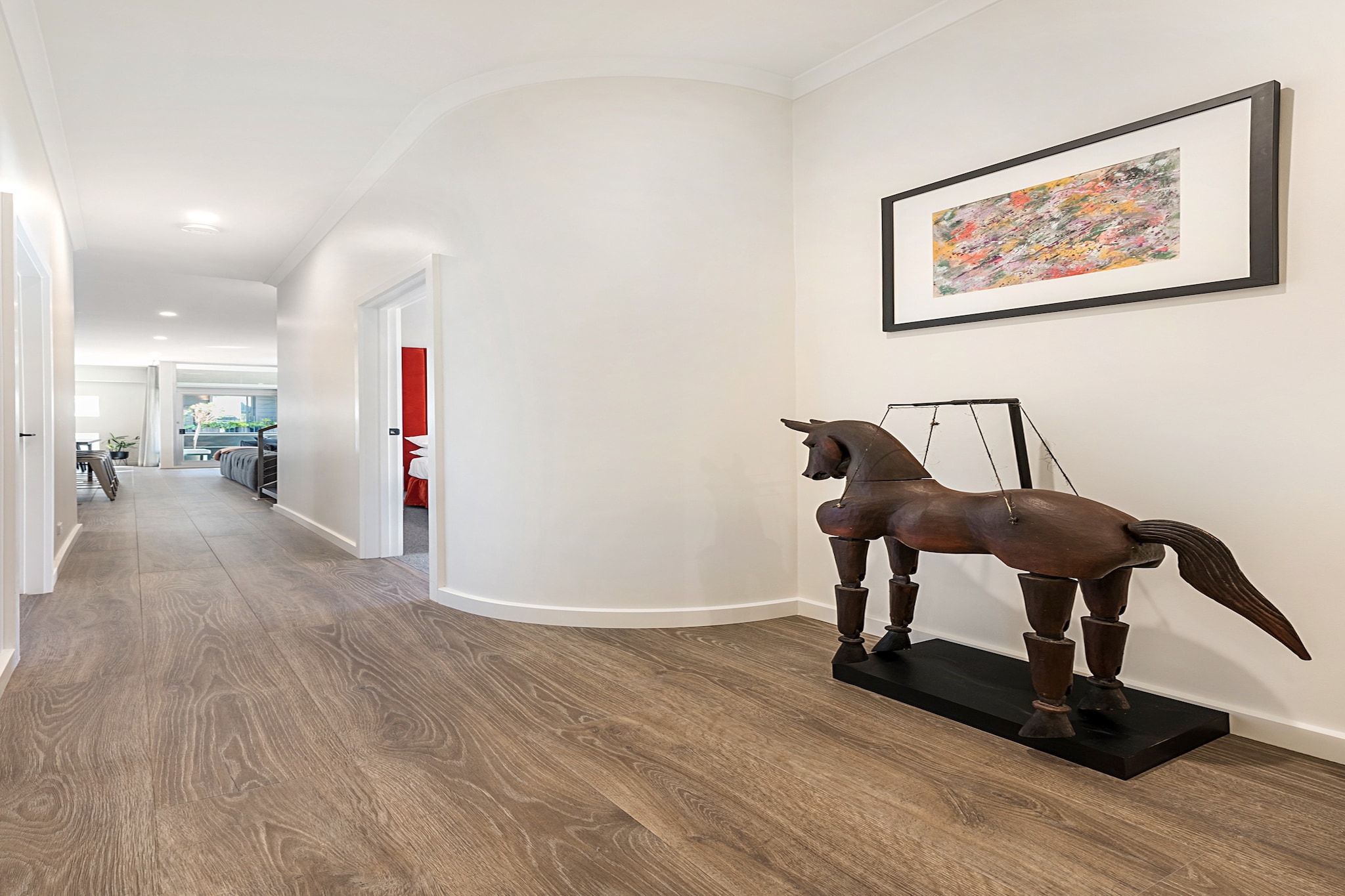 This is a spacious duplex apartment, in the heart of Fitzroy’s shopping, dining and nightlife along Brunswick, Gertrude and Smith St. It has an enormous living and dining area with plush lounges, high-quality entertainment and an adjoining balcony. The kitchen is with integrated upmarket appliances and a breakfast bar. The unit has a second level with an open bedroom, ensuite, balcony and desk, along with two bedrooms and bathrooms on the first level.
The space
Spread across two levels, this is an extravagant duplex apartment with timber floors, marble finishes and benchtops, and plush designer furnishings. It has two bedrooms and bathrooms on the first floor, one with a walk-in-wardrobe and ensuite, along with a designer kitchen, six-person dining, a comfy sofa and armchairs, and a balcony. Floating stairs lead up to the second level, which is essentially a retreat with a bedroom, wardrobe, ensuite, desk and sunny balcony.
 
General
- Entire 3-bedroom, 3-bathroom apartment
- 2 furnished balconies
- Air conditioning
- Laundry facilities provided
- Wi-Fi provided
- Study desk
- Heating
 
Living room
- Flat-screen TV
- Sofa
- Armchairs
- Coffee table
- Dining table
 
Bedrooms and bathrooms
- Bedroom 1: King-size bed, blackout blinds, walk-in wardrobe, ensuite, balcony
- Bedroom 2: Queen-size bed, blackout blinds, walk-in wardrobe, ensuite
- Bedroom 3: Double bed, blackout blinds, built-in wardrobe
- 3 bathrooms, including 2 ensuites
- Top quality linens & towels
 
Kitchen
- Modern stainless-steel appliances
- Electric oven and induction stovetop with rangehood
- Dishwasher
- Kettle, toaster, coffee machine and microwave
- Fridge and freezer
 
Laundry
- Iron and ironing board
- Washing machine and dryer
- Vacuum
- Clothes drying rack
 
Points of Interest
- Gertrude Street, 9 min walk, Smith Street, 5 min walk and Brunswick Street, 2 min walk
- Carlton Gardens 0.8 Km, ten-minutes walk or three-minutes drive
- Melbourne Museum 1.0 Km, 12-minutes walk or three-minutes drive
- Parliament House 1.5 Km, 19-minutes walk or five-minutes drive