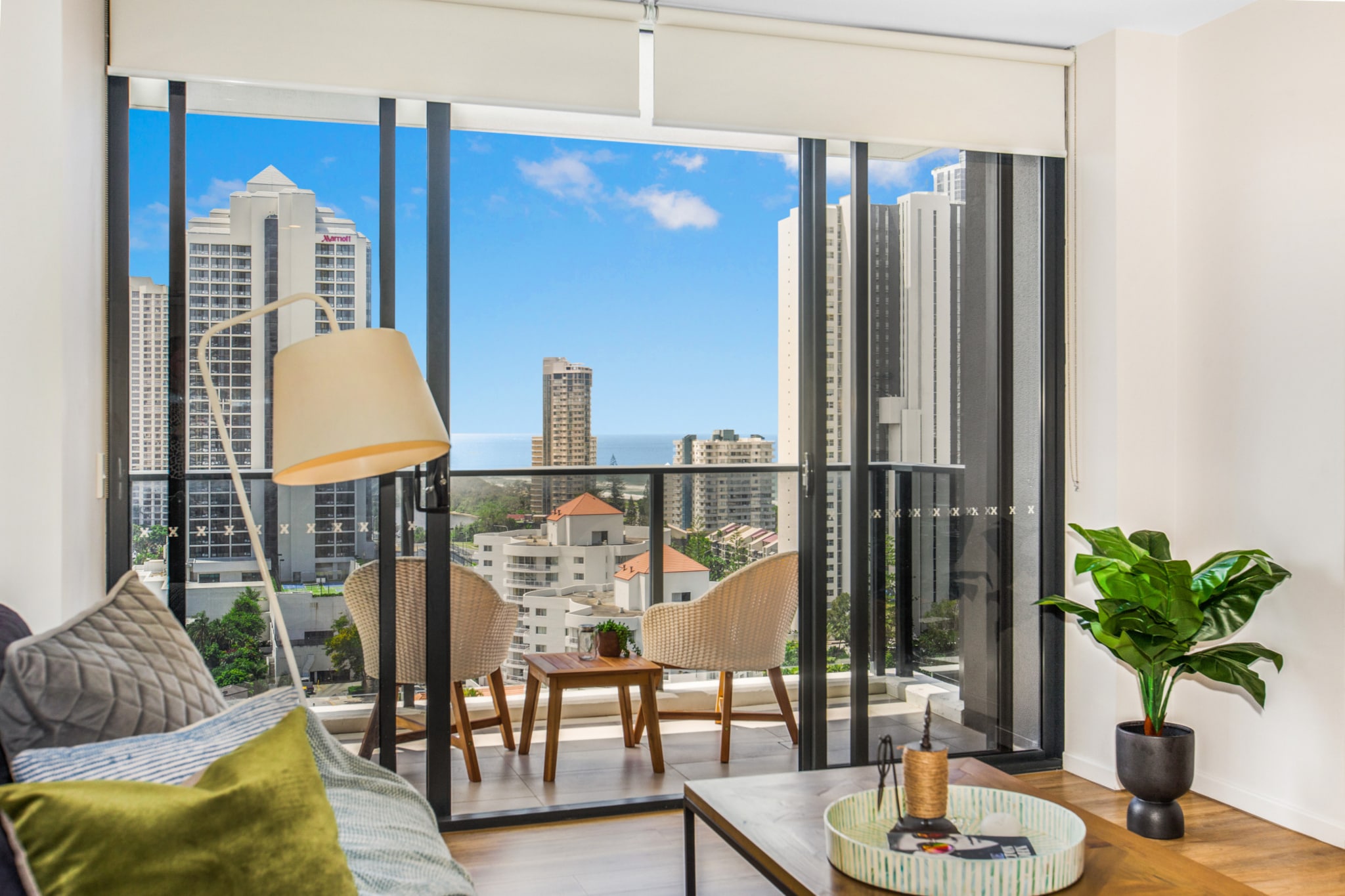 This apartment is ideal for family holidays on the Gold Coast. Resort-style facilities, including a gym, pool, sauna and barbecue, offer on-site recreation, while Surfers Paradise Beach is 500 metres away. Views of the city, river and ocean encircle the apartment, flowing into the bedrooms and open-plan living and dining room, where a well-equipped kitchen fosters social cooking. Relax on the furnished balcony and visit theme parks and wildlife attractions with the convenience of secure parking.
The space
This spacious apartment caters to families or groups seeking social living areas and private bedrooms. The two bedrooms have their own modern bathrooms, while the open-plan living and dining rooms combine with a furnished balcony and well-equipped kitchen to create an inviting hub of activity.
 
General
- Entire two-bedroom apartment
- Private furnished balcony with city and ocean views
- Communal pool, barbecue, sauna and gym
- Air conditioning
- Laundry facilities provided
- Wi-Fi
- Secure undercover parking
- Self check-in
 
Living room
- Flat-screen TV with Netflix
- Sofa
- Coffee table
- Dining table
 
Bedrooms and bathrooms
- Bedroom 1: Queen-size bed, blackout blinds
- Bedroom 2: Queen-size bed, blackout blinds
- 2 bathrooms, including one with shower bath
- Top quality linens & towels
 
Kitchen
- Stainless-steel appliances
- Electric oven and gas stove top with range hood
- Dishwasher
- Toaster, kettle, coffee machine and microwave
- Large fridge and freezer
 
Laundry
- Iron and ironing board
- Washing machine and dryer
- Clothes drying rack