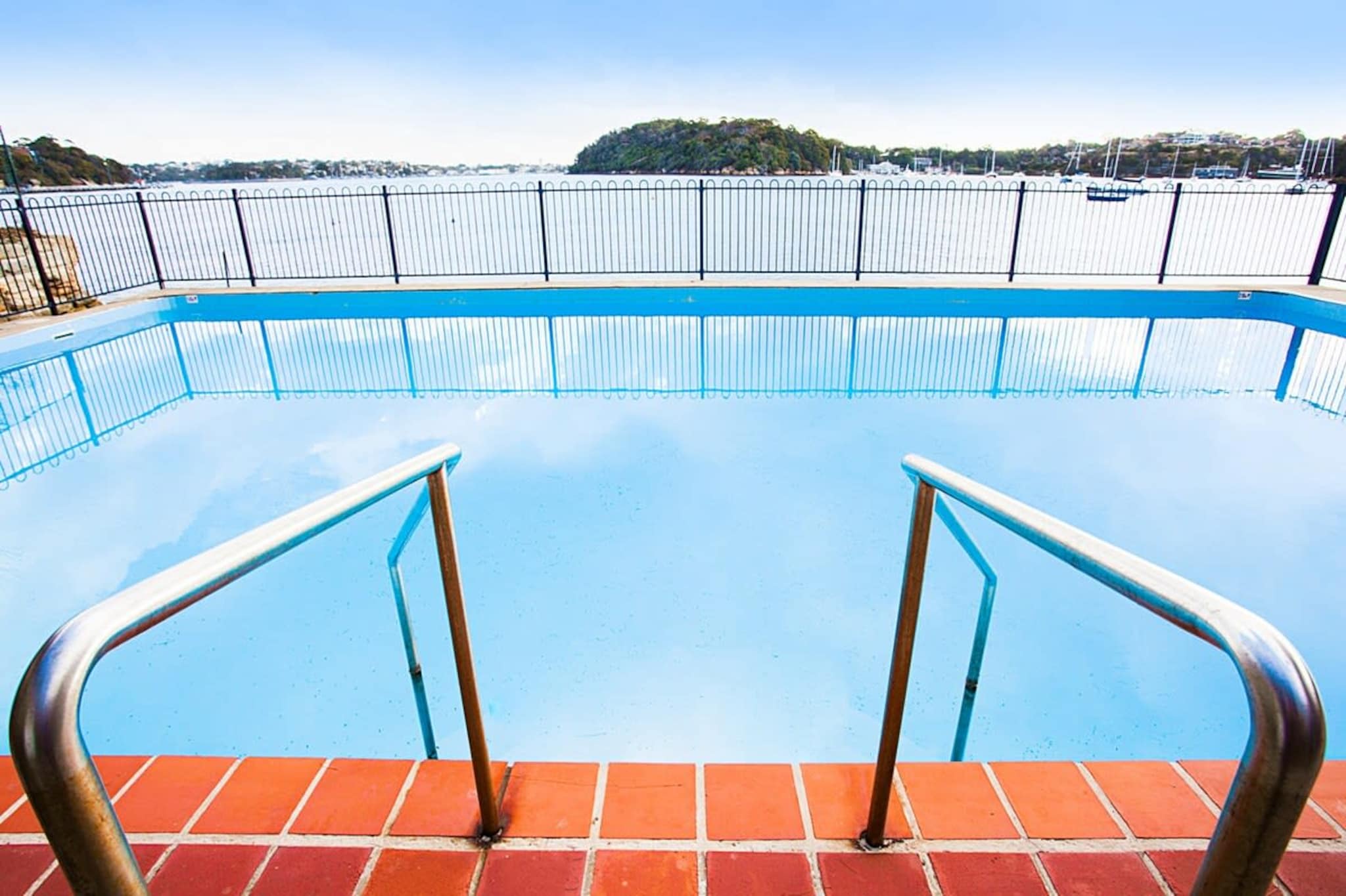 Could there be a more Sydney experience than sitting on the balcony of an elegant apartment drinking a glass of wine and watching the sun sets over the harbour? With its close-up view of Walsh Bay, hardwood floors, high ceilings and artistic touches, this property is an Instagrammer’s dream. It’s spacious and comfortable for a 1 bedroom, separate study, and is only minutes away from the city’s dining, shopping and nightlife thanks to McMahons Point Ferry Wharf, which is just around the corner
The space
Set in a classic brick apartment block, this one-bedroom & separate study apartment is light, airy and arty. The bedroom opens onto a spectacular balcony right on the harbour. The living room features a large picture window of the same view, and the property features original floorboards throughout.
 
General
-Elegantly decorated, with artworks, high ceilings and original floorboards
-Spectacular balcony with BBQ and outdoor seating
-Harbourside pool & gardens
-Study, separate & well-sized
-Air conditioning and heating (New Daikin heat pump just installed)
-Laundry facilities provided Washing machine provided & drying rack
-Wi-Fi provided
-No elevator available. Three flights of stairs to access the property
 
Living room
-Flat-screen TV
-Comfy furniture and dining setting for six
 
Bedrooms and bathrooms
-Bedroom 1: Queen bed, balcony access, blackout blinds
-Bathroom/Laundry with tub, shower, washing machine and luxe toiletries
-Top quality linen & towels
 
Kitchen
-Electric cooktop
-Miele appliances
-Dishwasher
-Coffee machine
-Microwave
-Newly renovated kitchen
 
Public transport
Ferries to the CBD, Barangaroo, Darling Harbour, Rose Bay & Pyrmont leave from McMahons Point Wharf, just down the road. - less than a 5 min walk
Bus stop within 3 minute walk
 
Ride sharing
Ride sharing apps are a safe and easy way to get around Sydney, especially later at night when public transport services are less frequent. Prices are about two-thirds that of taking a taxi, but may surge during bad weather or public events.
 
Points of Interest
- Central Business District 4.6 Km, nine-minutes drive
- North Sydney Business District 1Km
- Harbour Bridge 3.3 Km, five-minutes drive
- McMahons Point Village
- Luna Park
- The Ensemble Theatre, Kirribilli
- Darling Harbour 10.1 Km, 14-minutes drive
 
Beach Access
- Bondi Beach 14 Km, 30-minutes drive
- Manly Beach 12 Km, 30-minutes drive
- Balmoral Beach - 6.4km
 
Airport Access
- Kingsford Smith Airport 17 Km, 30-minute drive
House rules
You are staying in a friendly and peaceful neighbourhood and we kindly ask you to respect the community and your surrounding neighbours. The following strict House Rules apply:
 
 
 
- No loud noise between 10 pm and 8 am
- No parties or antisocial behaviour
- No additional people are to access the property without our prior approval
- No pets are allowed in the property without approval
- No smoking is allowed at any times
- If you break something, please let us know
- To help protect all floor coverings do not wear any shoes inside the property
 
 
Please be aware that excessive noise such as amplified music, vocals or screaming or anti-social behaviour in the property or common areas can cause neighbours to complain to us, the Building Manager, Council Rangers or Police.
 
 
IMPORTANT: Any breach of the House Rules may lead to a $500 fine plus compensation for any cost/damage created and immediate eviction of the property.
 
 
Finally, when checking out, we kindly ask you for the following:
 
- Please leave all beds unmade
- Please clean up your dishes and put them away
- In case you have rearranged furniture, please put it back to the original location
- Please take out the rubbish and remember to use the right bins
- Please ensure all appliances, A/C and lights are off and doors and windows are closed
Interaction with guests
Welcome to MadeComfy! Our local team curates stays in exceptional Australian & New Zealand properties, ensuring style, comfort, and prime locations for discerning guests. We prioritise your needs to provide a memorable home-away-from-home experience. Explore our digital guidebooks for local recommendations, and don't hesitate to contact us throughout your stay. We're here to ensure your comfort – enjoy your stay with MadeComfy.
Notes
For your comfort, this property is prepared with professional-grade hotel-style linen, including a three-sheet setup, ensuring a fresh and hygienic sleep experience.
 
Extra Services:
- Early check-in: Our standard check-in is at 3 pm. To guarantee early access to the property we suggest booking the night before if available. Otherwise, early check-in is subject to availability from the night before at an additional cost.
- Late check-out: Our standard check-out is at 10 am. To guarantee a later check-out of the property we suggest booking an additional night if available. Otherwise, a late check-out is subject to availability from the night before to an additional cost.
- Baggage: For security reasons, we are unable to receive or to keep unattended baggage before check-in or after check-out
- We provide a small welcome amenity pack to get your stay started
 
Note
- On-street parking is available with a one-hour parking restriction during business hours
- No elevator available. 3 flights of stairs to access the property
- Ring door bell on the front door. Does not have a view of the inside of the property.
- This booking is protected with coverage for lost baggage and emergency medical expenses, provided by Travel Support with claim upto 500 AUD (T&C Applies). For more details reach out to Guest Support team post booking.
Access description
You’ll have access to the entire property when you stay here, so it will feel like your own home.
Getting around
We highly recommend using ride-sharing services.
 
Check out the TripGo app for transport timetables.
 
Public transport
Ferries to the city leave from McMahons Point Wharf, just down the road.
 
Ride sharing
Ride sharing apps are a safe and easy way to get around Sydney, especially later at night when public transport services are less frequent. Prices are about two-thirds that of taking a taxi, but may surge during bad weather or public events.
 
Points of Interest
- Harbour Bridge 3.3 Km, five-minutes drive
- Central Business District 4.6 Km, nine-minutes drive
- Darling Harbour 10.1 Km, 14-minutes drive
 
Beach Access
- Bondi Beach 14 Km, 30-minutes drive
- Manly Beach 12 Km, 30-minutes drive
 
Airport Access
- Kingsford Smith Airport 17 Km, 30-minutes drive
