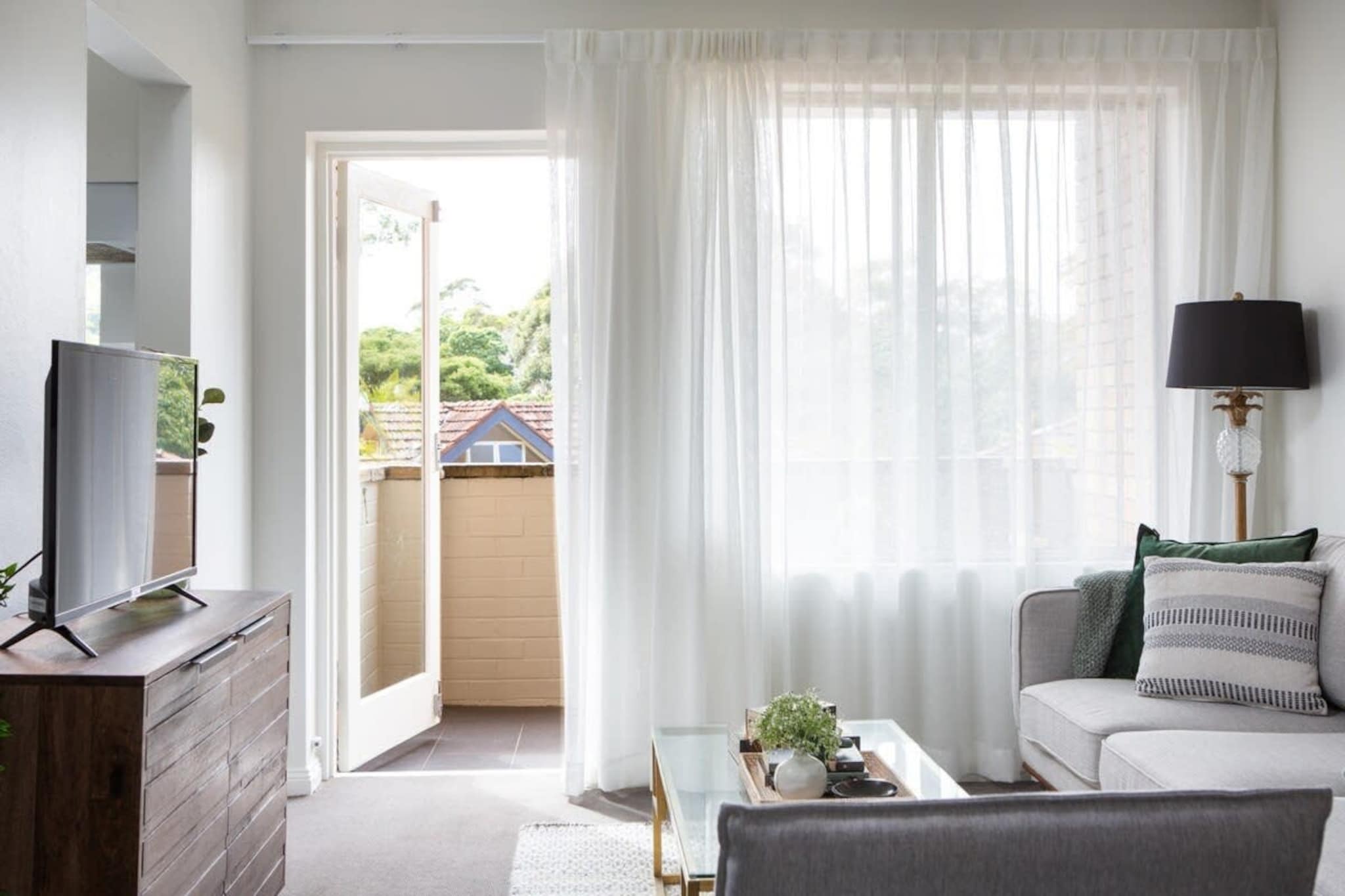 This lovely, light-filled unit in the leafy suburb of Lane Cove offers a tranquil retreat not far from the city. The CBD is only a 10 mins away, but you’d never know it from the local streets and parks filled with bowing gum trees. The area’s village-style shops, restaurants and local pubs are a convenient stroll away, and the apartment has everything you’ll need during your stay - including Parking. You’ll love the peace and quiet, as well as the generously proportioned, breezy living room.
The space
Part of a classic brick apartment block, this two-bedroom ground-floor apartment offers comfort, abundant natural light and stylish furniture. The building is positioned among leafy gardens, and the unit is tucked away from the road. There are three steps from street level into the property.
 
General
-Filled with light and artistic touches 
-Private balcony 
-Brick construction stays cool in summer and warm in winter 
-Washing machine and dryer
-Fans provided
-Wi-Fi provided 
-Free Parking available (suitable for small-medium cars)
 
Living room
-Flat-screen smart TV with Netflix (account needed)
-Comfy furniture and dining setting for four
-Opens onto balcony
 
Bedrooms and bathrooms
-Bedroom 1: Queen bed, built-in wardrobe, blackout blinds
-Bedroom 2: Queen bed, built-in wardrobe, blackout blinds
-Bathroom with shower, tub and luxe toiletries
-Top quality linen & towels
 
 
Kitchen
- Fully stocked with appliances
- Toaster, kettle, coffee machine and microwave
- Oven and electric cooktop available
 
Bathroom & Laundry
- Sleek bathroom
- Laundry unit available with a washer and a dryer
- Travel essentials, towels and hairdryer provided.
Points of Interest
- Harbour Bridge 9.5 Km, 10-minutes drive
- Central Business District 10.9 Km, 15-minutes drive
- Darling Harbour 15.7 Km, 17-minutes drive
- Greenwich Baths 4.0 Km, seven-minutes drive
- Lane Cove Golf Course 0.5 Km, six-minutes walk
- Lane Cove Tennis Club 0.6 Km, nine-minutes walk
- Lane Cove Aquatic Centre 0.7 Km, nine-minutes walk
- Via Napoli Pizzeria 0.3 Km, four-minutes walk
- Longueville Sports Club 0.5 Km, seven-minutes walk
- Longueville Hotel 0.7 Km, eight-minutes walk
- Anytime Fitness Gym 0.7 Km, eight-minutes walk
 
Beach Access
- Balmoral Beach 8.6 Km, ten-minutes drive
- Manly Beach 16.1 Km, 30-minutes drive
 
Airport Access
- Kingsford Smith Airport 24 Km, 28-minutes drive
House rules
You are staying in a friendly and peaceful neighbourhood and we kindly ask you to respect the community and your surrounding neighbours. The following strict House Rules apply:
 
- No loud noise between 10 pm and 8 am
- No parties or antisocial behaviour
- No additional people are to access the property without our prior approval
- No pets are allowed in the property without approval
- No smoking is allowed at any times
- If you break something, please let us know
- To help protect all floor coverings do not wear any shoes inside the property
 
 
Please be aware that excessive noise such as amplified music, vocals or screaming or anti-social behaviour in the property or common areas can cause neighbours to complain to us, the Building Manager, Council Rangers or Police.
 
 
IMPORTANT: Any breach of the House Rules may lead to a $500 fine plus compensation for any cost/damage created and immediate eviction of the property.
 
 
Finally, when checking out, we kindly ask you for the following:
 
- Please leave all beds unmade
- Please clean up your dishes and put them away
- In case you have rearranged furniture, please put it back to the original location
- Please take out the rubbish and remember to use the right bins
- Please ensure all appliances, A/C and lights are off and doors and windows are closed
Interaction with guests
Welcome to MadeComfy! Our local team curates stays in exceptional Australian & New Zealand properties, ensuring style, comfort, and prime locations for discerning guests. We prioritise your needs to provide a memorable home-away-from-home experience. Explore our digital guidebooks for local recommendations, and don't hesitate to contact us throughout your stay. We're here to ensure your comfort – enjoy your stay with MadeComfy.
Notes
For your comfort, this property is prepared with professional-grade hotel-style linen, including a three-sheet setup, ensuring a fresh and hygienic sleep experience.
 
Extra Services:
- Early check-in: Our standard check-in is at 3 pm. To guarantee early access to the property we suggest booking the night before if available. Otherwise, early check-in is subject to availability from the night before at an additional cost.
- Late check-out: Our standard check-out is at 10 am. To guarantee a later check-out of the property we suggest booking an additional night if available. Otherwise, a late check-out is subject to availability from the night before to an additional cost.
- Baggage: For security reasons, we are unable to receive or to keep unattended baggage before check-in or after check-out
- We provide a small welcome amenity pack to get your stay started
 
Note
- Parking is only suitable for small-medium cars.
- There are stairs inside the property.
- Please be advised the hot water heater is 50L so has limited usage time.
- Heating provided is by portable electric heaters.
- Smoking on the balcony is prohibited.
- Pets allowed upon approved requests, additional fees apply
- This booking is protected with coverage for lost baggage and emergency medical expenses, provided by Travel Support with claim upto 500 AUD (T&C Applies). For more details reach out to Guest Support team post booking.
Access description
You’ll have access to the entire property when you stay here, so it will feel like your own home. Keys are 24 hours available.
Getting around
Getting Arround
 
We highly recommend using ride-sharing services.
 
Check out the TripGo app for transport timetables.
 
Public transport
Buses to the city leave at the end of Longueville Rd, a 10-minute walk, and take between 10 and 15 minutes to get to the city.
 
Ride sharing
Ride sharing apps are a safe and easy way to get around, especially later at night when public transport services are less frequent. Prices are about two-thirds that of taking a taxi, but may surge during bad weather or public events.
