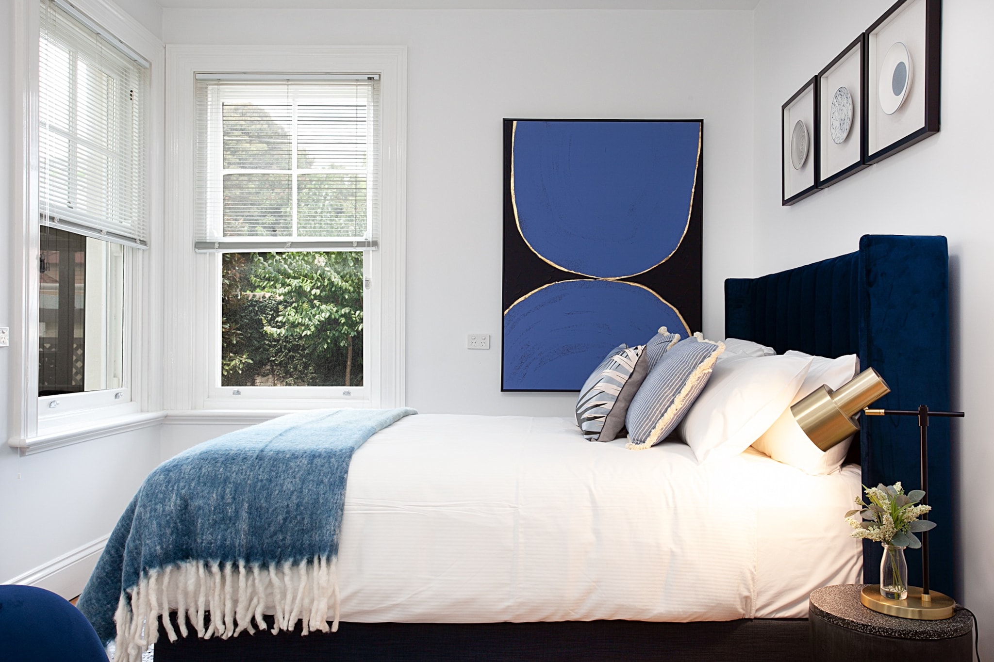 Located in a huge Edwardian villa on a grand tree-lined street in the Inner West suburb of Lewisham, this studio apartment combines the best of old and new. The front fountain, staircase and manicured lawn point to the building’s historical significance, but inside visitors are treated to contemporary interior design, new appliances and arty touches. A private courtyard provides airflow and a place to relax, while features like an internal laundry and wall-mounted TV add comfort and convenience.

The space
This ground floor studio has a lot going for it. For starters, lots of light and air through multiple windows and a door onto a private courtyard with outdoor furniture. And unlike many other studio apartments, it has a separate living area – no need to watch TV in bed. The kitchen is full-size and fully equipped, and there’s even an internal laundry. There are three steps from street level to the apartment.
 
General
- Heritage touches including high ceilings and wooden floors
- Secure building with intercom access
- Private courtyard with outdoor furniture
- Contemporary furniture and original artworks
- Washing machine and drying rack provided
- Wi-Fi
- Self check-in
 
Studio
- Flat-screen wall-mounted TV
- Sofa and two-person dining setting
- Opens onto courtyard
- Stylish bathroom with checkerboard tiles, shower and luxe toiletries
- Top quality linen & towels
 
Kitchen
- Electric cooktop
- Modern stainless-steel appliances
- Dishwasher
- Coffee machine
Local area description
Located in Sydney’s trendy Inner West, Lewisham is a relaxed residential suburb characterised by Victorian and Edwardian mansions, post-war apartments and quiet streets. Young families and older residents are attracted by its access to the Light Rail and Sydney Trains, as well as its convenient location near the city and the airport. It’s also close to some great dining and entertainment areas, including New Canterbury Road, Norton St and Marrickville Road.
House rules
You are staying in a friendly and peaceful neighbourhood and we kindly ask you to respect the community and your surrounding neighbours. The following strict House Rules apply:
- No loud noise between 10 pm and 8 am
- No parties or antisocial behaviour
- No additional people are to access the property without our prior approval
- No pets are allowed in the property without approval
- No smoking is allowed at any times
- If you break something, please let us know
- To help protect all floor coverings do not wear any shoes inside the property
 
Please be aware that excessive noise such as amplified music, vocals or screaming or anti-social behaviour in the property or common areas can cause neighbours to complain to us, the Building Manager, Council Rangers or Police.
 
IMPORTANT: Any breach of the House Rules may lead to a $500 fine plus compensation for any cost/damage created and immediate eviction of the property.
 
Finally, when checking out, we kindly ask you for the following:
- Please leave all beds unmade
- Please clean up your dishes and put them away
- In case you have rearranged furniture, please put it back to the original location
- Please take out the rubbish and remember to use the right bins
- Please ensure all appliances, A/C and lights are off and doors and windows are closed
Interaction with guests
Welcome to MadeComfy! Our local team curates stays in exceptional Australian & New Zealand properties, ensuring style, comfort, and prime locations for discerning guests. We prioritise your needs to provide a memorable home-away-from-home experience. Explore our digital guidebooks for local recommendations, and don't hesitate to contact us throughout your stay. We're here to ensure your comfort – enjoy your stay with MadeComfy.
Notes
For your comfort, this property is prepared with professional-grade hotel-style linen, including a three-sheet setup, ensuring a fresh and hygienic sleep experience.
 
Extra Services:
- Early check-in: Our standard check-in is at 3 pm. To guarantee early access to the property we suggest booking the night before if available. Otherwise, early check-in is subject to availability from the night before at an additional cost.
- Late check-out: Our standard check-out is at 10 am. To guarantee a later check-out of the property we suggest booking an additional night if available. Otherwise, a late check-out is subject to availability from the night before to an additional cost.
- Baggage: For security reasons, we are unable to receive or to keep unattended baggage before check-in or after check-out
- We provide a small welcome amenity pack to get your stay started
- This booking is protected with coverage for lost baggage and emergency medical expenses, provided by Travel Support with claim upto 500 AUD (T&C Applies). For more details reach out to Guest Support team post booking.
Access description
You’ll have access to the entire property when you stay here, so it will feel like your own home.
- The keys will be left in a lockbox onsite. We will send you the access code 3 days prior to your arrival.
Getting around
We highly recommend using ride-sharing services.
 
Check out the TripGo app for transport timetables.
 
Public transport
Lewisham Station is 10 minutes walk away. Trains to the city leave four times an hour and take 15 minutes. The light rail is even closer, providing access to the Inner West and Darling Harbour.
 
Ride sharing
Ride sharing apps are a safe and easy way to get around, especially later at night when public transport services are less frequent. Prices are about two-thirds that of taking a taxi, but may surge during bad weather or public events.
 
Points of Interest
- Norton St Restaurant Precinct 3.5 Km, five-minutes drive
- Central Business District 8.9 Km, 18-minutes drive
- Darling Harbour 12.1 Km, 28-minutes drive
 
Beach Access
- Bondi Beach 14.9 Km, 35-minutes drive
 
Airport Access
- Kingsford Smith Airport 8.1 Km, 18-minutes drive