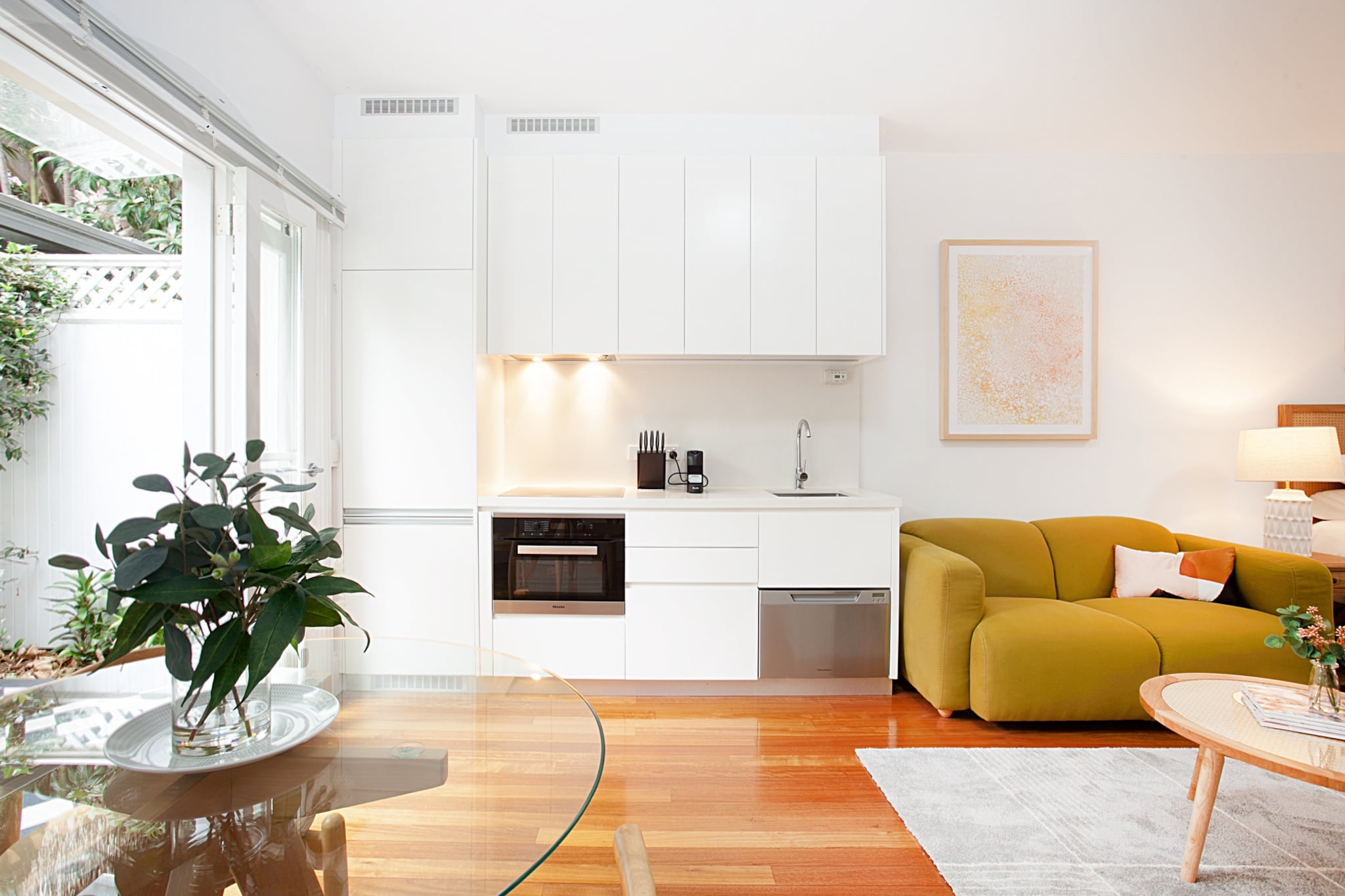 Boasting a beautiful, yet peaceful and private location, you’ll be spoilt for choice when it comes to the very best restaurants, entertainment venues, cafes, and shops the inner west has on offer. An easy walk to Lewisham Station and main bus routes, you’ll find that this conveniently located home is also well-equipped for trips on the weekends or weeks on end. But, whatever you do, don't miss a chance to use the blackout blinds for the best sleep of your life.

The space
Located in a lovely tree lined street, this new studio is in a prime location, within walking distance to Lewisham Station, multiple bus routes, parklands and shops. Boasting a versatile floorplan, quality finishes throughout, it sleeps up to 2 guests, and has a spacious balcony.
 
General
- Contemporary styling and furniture
- Two common areas - shared media/study room and sitting room
- Quality sheets and towels
- Courtyard for alfresco dining
- Wi-Fi is provided
- Self check-in
 
Kitchen/dining
- Kitchen fitted with Miele appliances including oven/microwave, cook top, dishwasher, coffee machine, integrated two door refrigerator
- Well-stocked with utensils for cooking own meals
 
Living/dining room
- Bright open space with large windows
- Comfortable and spacious lounge and dining setting
- Flat-screen LCD TV
 
Bathroom
- Spacious bathroom with toiletries and towels provided
- Travel essentials and hairdryer provided
- Beautiful showers
 
Bedrooms
- Blackout blinds in every bedroom
- One Queen bed
- Built in robe and ample storage space available
Local area description
When you’ve spent your day navigating the urban chaos, there’s nothing better than returning to a space of peace and tranquillity. Lewisham provides the perfect chill out zone in the heart of the Inner West.This peaceful pocket should not be overlooked by those seeking convenience, character and a friendly communal vibe.
 
The leafy little suburb features long boulevards lined with graceful family homes, cute cottages and spacious apartments. Excellent schools and a safe, relaxed atmosphere make Lewisham outstanding for families. With a train station, a light rail stop and numerous bus services, Lewisham is also perfect for anyone who dreams of ditching their car.
 
Just beyond Lewisham’s borders lie many more attractions. Leichardt’s famous Italian restaurants are a short stroll to the north, Summer Hill’s cafes lie to the west, while the Portuguese eateries of Petersham’s Little Lisbon are just to the east. Petersham Oval provides a picturesque place to relax and will forever be famous as the place where Don Bradman scored his very first club runs.
House rules
You are staying in a friendly and peaceful neighbourhood and we kindly ask you to respect the community and your surrounding neighbours. The following strict House Rules apply:
- No loud noise between 10 pm and 8 am
- No parties or antisocial behaviour
- No additional people are to access the property without our prior approval
- No pets are allowed in the property without approval
- No smoking is allowed at any times
- If you break something, please let us know
 
- To help protect all floor coverings do not wear any shoes inside the property
 
Please be aware that excessive noise such as amplified music, vocals or screaming or anti-social behaviour in the property or common areas can cause neighbours to complain to us, the Building Manager, Council Rangers or Police.
 
IMPORTANT: Any breach of the House Rules may lead to a $500 fine plus compensation for any cost/damage created and immediate eviction of the property.
 
Finally, when checking out, we kindly ask you for the following:
- Please leave all beds unmade
- Please clean up your dishes and put them away
- In case you have rearranged furniture, please put it back to the original location
- Please take out the rubbish and remember to use the right bins
- Please ensure all appliances, A/C and lights are off and doors and windows are closed
Interaction with guests
Welcome to MadeComfy! Our local team curates stays in exceptional Australian & New Zealand properties, ensuring style, comfort, and prime locations for discerning guests. We prioritise your needs to provide a memorable home-away-from-home experience. Explore our digital guidebooks for local recommendations, and don't hesitate to contact us throughout your stay. We're here to ensure your comfort – enjoy your stay with MadeComfy.
Notes
For your comfort, this property is prepared with professional-grade hotel-style linen, including a three-sheet setup, ensuring a fresh and hygienic sleep experience.
 
Extra Services:
- Early check-in: Our standard check-in is at 3 pm. To guarantee early access to the property we suggest booking the night before if available. Otherwise, early check-in is subject to availability from the night before at an additional cost.
- Late check-out: Our standard check-out is at 10 am. To guarantee a later check-out of the property we suggest booking an additional night if available. Otherwise, a late check-out is subject to availability from the night before to an additional cost.
- Baggage: For security reasons, we are unable to receive or to keep unattended baggage before check-in or after check-out
- We provide a small welcome amenity pack to get your stay started
- This booking is protected with coverage for lost baggage and emergency medical expenses, provided by Travel Support with claim upto 500 AUD (T&C Applies). For more details reach out to Guest Support team post booking.
Access description
You’ll have access to the entire property when you stay here, so it will feel like your own home.
- The keys will be left in a lockbox onsite. We will send you the access code 3 days prior to your arrival.
Getting around
We highly recommend using ride-sharing services.
 
Check out the TripGo app for transport timetables.
 
Points of Interest
- Norton St Restaurant Precinct 3.5 Km, five-minutes drive
- Central Business District 8.9 Km, 18-minutes drive
- Darling Harbour 12.1 Km, 28-minutes drive
 
Beach Access
- Bondi Beach 14.9 Km, 35-minutes drive
 
Airport Access
- Kingsford Smith Airport 8.1 Km, 18-minutes drive