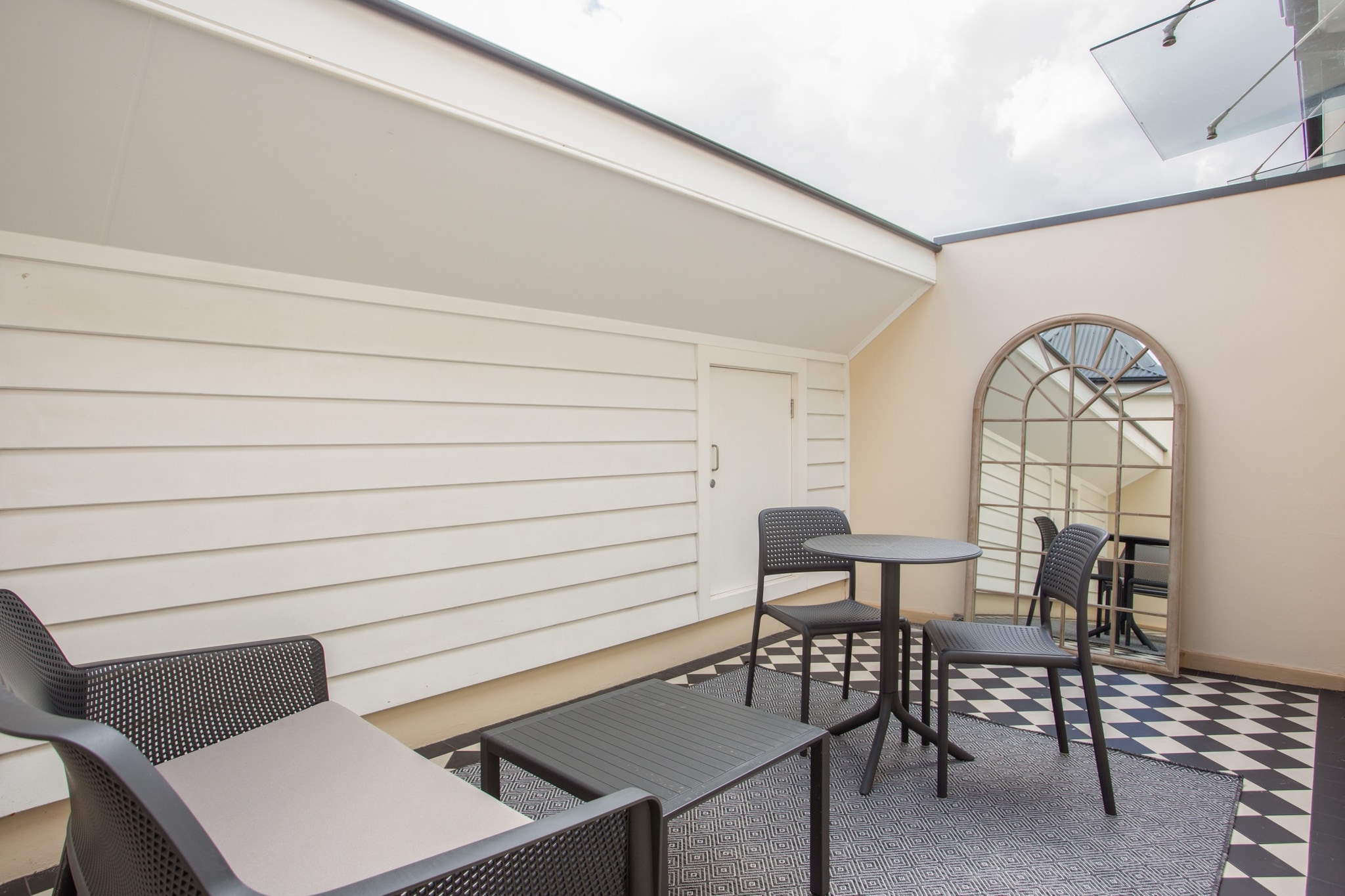 Stay in the peaceful suburb of Lewisham, only a few minutes’ walk from the bars, cafes, restaurants and boutiques along New Canterbury Road. This elegant studio is a delightful retreat in a grand manor house. It emphasises comfort with its plush bedding and lounge seating, high-end appliances and contemporary decor. It has a well-equipped kitchen and a spacious terrace ideal for alfresco dining. Nearby trains and trams offer easy transport to the Sydney CBD and beaches.
The space
This is a cosy studio space with polished timber floors, French doors and sleek finishes. It has high-end appliances in its laundry and kitchen, comfortable furnishings and an overall sense of style and sophistication. The alfresco terrace is an alluring area for dining and drinks on sunny days.
 
General
- Entire studio apartment
- Private furnished terrace
- Laundry facilities provided
- Wi-Fi is available
- Portable fan/heater
- Communal lounge room
- Self check-in
 
Living room
- Flat-screen TV
- Sofa
- Coffee table
- Dining table
 
Bedrooms and bathrooms
- Bedroom: Queen-size bed, blackout blinds, desk
- One bathroom with hairdryer
- Top quality linens & towels
 
Kitchen
- Miele appliances
- Combination microwave/oven and induction stovetop with rangehood
- Toaster, kettle and coffee machine
- Fridge and freezer
- Dishwasher
 
Laundry
- Combination washer and dryer
- Clothes drying rack
- Iron and ironing board
Local area description
Located within 20 minutes from the Sydney CBD and Sydney Airport, Lewisham is ideally located for visitors seeking suburban tranquillity and inner-city convenience. The suburb has light-rail and subway stations, along with neighbouring restaurant and cafe strips along New Canterbury Road. Lewisham borders the Hawthorne Canal, which runs through the leafy Cadigal Reserve.
House rules
You are staying in a friendly and peaceful neighbourhood and we kindly ask you to respect the community and your surrounding neighbours. The following strict House Rules apply:
- No loud noise between 10 pm and 8 am
- No parties or antisocial behaviour
- No additional people are to access the property without our prior approval
- No pets are allowed in the property without approval
- No smoking is allowed at any times
- If you break something, please let us know
 
- To help protect all floor coverings do not wear any shoes inside the property
 
Please be aware that excessive noise such as amplified music, vocals or screaming or anti-social behaviour in the property or common areas can cause neighbours to complain to us, the Building Manager, Council Rangers or Police.
 
IMPORTANT: Any breach of the House Rules may lead to a $500 fine plus compensation for any cost/damage created and immediate eviction of the property.
 
Finally, when checking out, we kindly ask you for the following:
- Please leave all beds unmade
- Please clean up your dishes and put them away
- In case you have rearranged furniture, please put it back to the original location
- Please take out the rubbish and remember to use the right bins
- Please ensure all appliances, A/C and lights are off and doors and windows are closed
Interaction with guests
Welcome to MadeComfy! Our local team curates stays in exceptional Australian & New Zealand properties, ensuring style, comfort, and prime locations for discerning guests. We prioritise your needs to provide a memorable home-away-from-home experience. Explore our digital guidebooks for local recommendations, and don't hesitate to contact us throughout your stay. We're here to ensure your comfort – enjoy your stay with MadeComfy.
Notes
For your comfort, this property is prepared with professional-grade hotel-style linen, including a three-sheet setup, ensuring a fresh and hygienic sleep experience.
 
Extra Services:
- Early check-in: Our standard check-in is at 3 pm. To guarantee early access to the property we suggest booking the night before if available. Otherwise, early check-in is subject to availability from the night before at an additional cost.
- Late check-out: Our standard check-out is at 10 am. To guarantee a later check-out of the property we suggest booking an additional night if available. Otherwise, a late check-out is subject to availability from the night before to an additional cost.
- Baggage: For security reasons, we are unable to receive or to keep unattended baggage before check-in or after check-out
- We provide a small welcome amenity pack to get your stay started
 
Note
-The communal lounge room is on the ground floor
-There is a basement for storing bicycles and luggage
-Only a portable fan/heater
- This booking is protected with coverage for lost baggage and emergency medical expenses, provided by Travel Support with claim upto 500 AUD (T&C Applies). For more details reach out to Guest Support team post booking.
Access description
You’ll have access to the entire property when you stay here, so it will feel like your own home.
- The keys will be left in a lockbox onsite. We will send you the access code 3 days prior to your arrival.
Getting around
We highly recommend using ride-sharing services.
 
Check out the TripGo app for transport timetables.
 
Public transport
The Lewisham train station is about 800 metres away and has regular trains into the Sydney CBD in around 15 minutes. The Lewisham West light-rail station is 900 metres away and has services to the Sydney CBD in 30 minutes. There are also bus stops along New Canterbury Road with multiple lines servicing the CBD and surrounding suburbs.
 
Ride sharing
Ride sharing apps are a safe and easy way to get around, especially late at night when public transport services are less frequent. Prices are about two-thirds of a taxi, but may surge during bad weather or public events.
 
Points of Interest
- Marrickville Park 1.0 Km, 13-minutes walk or three-minutes drive
- The Factory Theatre 3.0 Km, 36-minutes walk or six-minutes drive
- Canterbury Park Racecourse 4.6 Km, 45-minutes walk or eight-minutes drive
 
Beach Access
- Coogee Beach 12.9 Km, 22-minutes drive
- Bondi Beach 17.1 Km, 17-minutes drive
 
Airport Access
- Sydney Airport 10.4 Km, 17-minutes drive