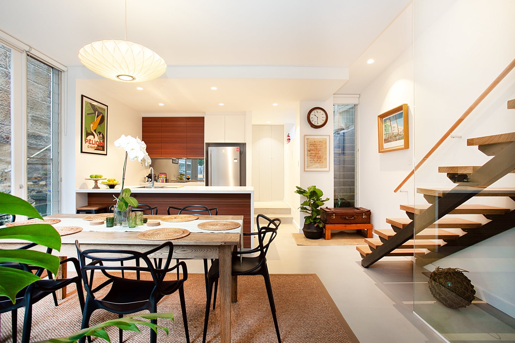 Up to six guests can stay in this inviting home, which has two bathrooms and three bedrooms, including one with single beds. The two-storey house has ample space for families to relax. Watch movies in the cosy living room, socialise around the six-seat dining table and cook up a feast in the modern kitchen. The upper floor has a balcony, while the courtyard boasts a hammock and lush garden. The house is close to Balmainâ€™s downtown with Balmain Market, Gladstone Park and various dining options.
The space
Set across two storeys, this charming home caters to large families with three bedrooms and two bathrooms. It accommodates little ones with single beds and a shower bath. The downstairs living and dining area is spacious and filled with comfortable furnishings, while the open kitchen features high-end appliances. It also offers outdoor living with a garden courtyard and upstairs balcony.
 
General
-Entire three-bedroom, two-bathroom house
-Private upstairs balcony
-Courtyard with garden and hammock
-Laundry facilities provided
-Wi-Fi is available
-No air conditioning
-Self check-in
 
Living room
-Flat-screen TV
-Sofa and armchairs
-6-seat dining table
-Coffee table
 
Bedrooms and bathrooms
-Bedroom 1: Queen bed, balcony with city views, built-in wardrobe, blackout blinds
-Bedroom 2: Double bed, wardrobe, blackout blinds
-Bedroom 3: 2 single beds, built-in wardrobe
-2 bathrooms, including one with rain shower and one with shower bath
-Top quality linens & towels
 
Kitchen
-Stainless-steel appliances
-Electric oven and induction stovetop with rangehood
-Dishwasher
-Toaster, kettle, coffee machine and microwave
-Fridge and freezer
 
Laundry
-Washing machine and dryer
-Iron and ironing board
-Clothes drying rack
Local area description
About 15 minutes from the Sydney CBD, Balmain is an attractive neighbourhood filled with Victorian-era houses, alfresco cafes and lush parks. Itâ€™s home to a popular restaurant scene, which is best experienced along Darling Street, along with fashionable boutiques, artisan bakeries and cosmopolitan eateries. Visit the Balmain Market on weekends for handicrafts and organic goods and venture north or east to relax at waterside parks.
House rules
You are staying in a friendly and peaceful neighbourhood and we kindly ask you to respect the community and your surrounding neighbours. The following strict House Rules apply:
 
- No loud noise between 10 pm and 8 am
- No parties or antisocial behaviour
- No additional people are to access the property without our prior approval
- No pets are allowed in the property without approval
- No smoking is allowed at any times
- If you break something, please let us know
- To help protect all floor coverings do not wear any shoes inside the property
 
Please be aware that excessive noise such as amplified music, vocals or screaming or anti-social behaviour in the property or common areas can cause neighbours to complain to us, the Building Manager, Council Rangers or Police.
 
IMPORTANT: Any breach of the House Rules may lead to a $500 fine plus compensation for any cost/damage created and immediate eviction of the property.
 
Finally, when checking out, we kindly ask you for the following:
 
- Please leave all beds unmade
- Please clean up your dishes and put them away
- In case you have rearranged furniture, please put it back to the original location
- Please take out the rubbish and remember to use the right bins
- Please ensure all appliances, A/C and lights are off and doors and windows are closed
Interaction with guests
Welcome to MadeComfy! Our local team curates stays in exceptional Australian & New Zealand properties, ensuring style, comfort, and prime locations for discerning guests. We prioritise your needs to provide a memorable home-away-from-home experience. Explore our digital guidebooks for local recommendations, and don't hesitate to contact us throughout your stay. We're here to ensure your comfort â€“ enjoy your stay with MadeComfy.
Notes
For your comfort, this property is prepared with professional-grade hotel-style linen, including a three-sheet setup, ensuring a fresh and hygienic sleep experience.
 
Extra Services:
- Early check-in: Our standard check-in is at 3 pm. To guarantee early access to the property we suggest booking the night before if available. Otherwise, early check-in is subject to availability from the night before at an additional cost.
- Late check-out: Our standard check-out is at 10 am. To guarantee a later check-out of the property we suggest booking an additional night if available. Otherwise, a late check-out is subject to availability from the night before to an additional cost.
- Baggage: For security reasons, we are unable to receive or to keep unattended baggage before check-in or after check-out
- We provide a small welcome amenity pack to get your stay started
 
Notes:
- There is ongoing construction in the area, which may create noise during your stay.
- Bins are located outside the sliding glass door in the dining room
- Unlimited street parking available on Cooper Street and St Andrews Street
- Parking in the courtyard of the property is prohibited.
- CCTV cameras in common outside areas. Front Door, Back of property and lockbox. area
- Access to the backyard is not available to guests. The courtyard can be used as an alternative.
- This booking is protected with coverage for lost baggage and emergency medical expenses, provided by Travel Support with claim upto 500 AUD (T&C Applies). For more details reach out to Guest Support team post booking.
Access description
Youâ€™ll have access to the entire property when you stay here, so it will feel like your own home.
- The keys will be left in a lockbox onsite. We will send you the access code 3 days prior to your arrival.
Getting around
We highly recommend using ride-sharing services.
 
Check out the TripGo app for transport timetables.
 
Public transport
The Balmain Wharf ferry terminal is about 600 metres away and has regular ferries to Circular Quay and Darling Harbour. There are multiple bus stops along Darling Street with the line 442 servicing the surrounding suburbs and accessing the Sydney CBD in about 25 minutes.
 
Ride sharing
Ride sharing apps are a safe and easy way to get around, especially late at night when public transport services are less frequent. Prices are about two-thirds of a taxi, but may surge during bad weather or public events.
 
Points of Interest
- Gladstone Park Playground 0.5 Km, five-minutes walk or two-minutes drive
- Balmain Market 0.45 Km, five-minutes walk or two-minutes drive
- Mort Bay Park 0.7 Km, ten-minutes walk or four-minutes drive
 
Beach Access
- Bondi Beach 14 Km, 22-minutes drive
- Coogee Beach 14.5 Km, 22-minutes drive
 
Airport Access
- Sydney Airport 19.5 Km, 26-minutes drive