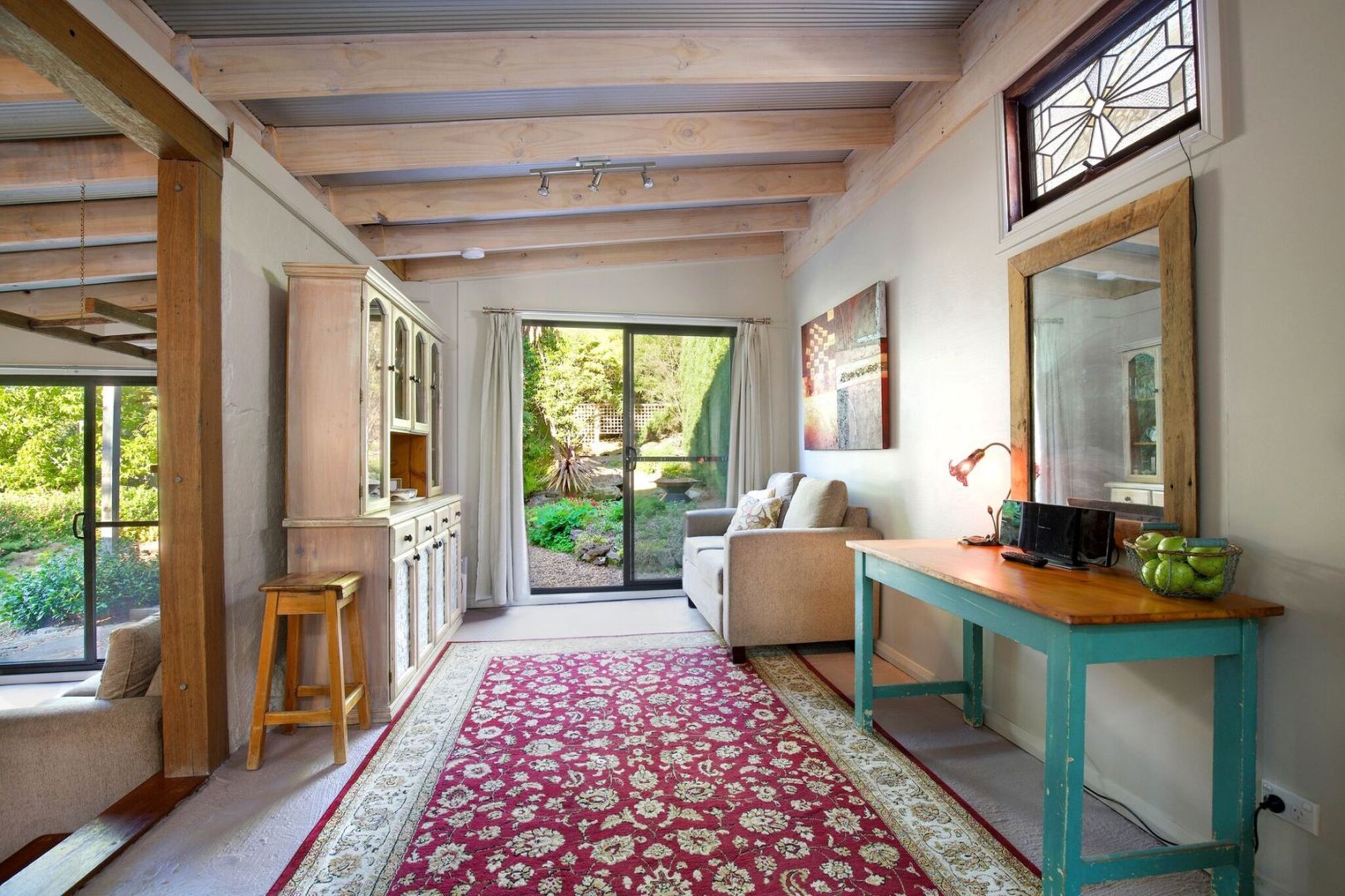 Little Haven Leura is a beautifully rustic cottage ideal for a romantic Blue Mountains holiday, located minutes from Leura Mall and popular lookouts and walks. The intimate hideaway has an open-plan layout featuring a cosy living room with a chandeliered bedroom with a king-size bed. Relax in the spa bath before dining on the private barbecue patio surrounded by plants and wildlife. A charming dining and sitting area also adjoins the well-equipped kitchen.
The space
Little Haven Leura is an open-plan cottage with comfortable furnishings in its sunlit living room, bedroom and dining room. Exposed timber beams, brick walls and timber finishes lend it rustic appeal. While the spa bath and private garden patio with a barbecue offer inviting luxury in the magnificent Blue Mountains.
 
General
- Entire Blue Mountains cottage
- Private garden patio with BBQ and seating
- Spa bath
- Parking is for small cars only.
- Washing machine provided
- Air conditioning
- Wi-Fi is provided
- Self check-in
 
Living room
- Flat-screen TV
- Sofa
 
Dining room
- Dining table
- Sofa
 
Bedrooms and bathrooms
- Bedroom: King bed
- Electric blanket in the bedroom
- Bathroom with spa bath and hairdryer
- Top quality linens & towels
 
Kitchen
- High-quality appliances
- Oven and stovetop with rangehood
- Dishwasher
- Microwave and coffee machine
- Large fridge and freezer
 
Laundry
- Washing machine
- Iron
Local area description
Alongside Katoomba, Leura is considered the heart of the Blue Mountains. This suburb is more of a charming township with a farm-to-table dining scene, boutique shopping and gourmet cafe culture centred around Leura Mall. It’s also home to inviting local attractions, such as a teapot museum and historic art deco home. Leura also boasts some of the most popular Blue Mountains lookouts and walking trails, including Gordon Falls and Lyrebird Dell.
House rules
You are staying in a friendly and peaceful neighbourhood and we kindly ask you to respect the community and your surrounding neighbours. The following strict House Rules apply:
- No loud noise between 10 pm and 8 am
- No parties or antisocial behaviour
- No additional people are to access the property without our prior approval
- No pets are allowed in the property without approval
- No smoking is allowed at any times
- If you break something, please let us know
 
- To help protect all floor coverings do not wear any shoes inside the property
 
Please be aware that excessive noise such as amplified music, vocals or screaming or anti-social behaviour in the property or common areas can cause neighbours to complain to us, the Building Manager, Council Rangers or Police.
 
IMPORTANT: Any breach of the House Rules may lead to a $500 fine plus compensation for any cost/damage created and immediate eviction of the property.
 
Finally, when checking out, we kindly ask you for the following:
- Please leave all beds unmade
- Please clean up your dishes and put them away
- In case you have rearranged furniture, please put it back to the original location
- Please take out the rubbish and remember to use the right bins
- Please ensure all appliances, A/C and lights are off and doors and windows are closed
Interaction with guests
Welcome to MadeComfy! Our local team curates stays in exceptional Australian & New Zealand properties, ensuring style, comfort, and prime locations for discerning guests. We prioritise your needs to provide a memorable home-away-from-home experience. Explore our digital guidebooks for local recommendations, and don't hesitate to contact us throughout your stay. We're here to ensure your comfort – enjoy your stay with MadeComfy.
Notes
For your comfort, this property is prepared with professional-grade hotel-style linen, including a three-sheet setup, ensuring a fresh and hygienic sleep experience.
 
Extra Services:
- Early check-in: Our standard check-in is at 3 pm. To guarantee early access to the property we suggest booking the night before if available. Otherwise, early check-in is subject to availability from the night before at an additional cost.
- Late check-out: Our standard check-out is at 10 am. To guarantee a later check-out of the property we suggest booking an additional night if available. Otherwise, a late check-out is subject to availability from the night before to an additional cost.
- Baggage: For security reasons, we are unable to receive or to keep unattended baggage before check-in or after check-out
- We provide a small welcome amenity pack to get your stay started
 
Note
- Luggage drop-off is allowed for early arrivals or late departures
- Private entrance
- For heating purposes, the cottage is equipped with reverse cycle air conditioning
- Pets allowed upon approved requests, additional fees apply
- This booking is protected with coverage for lost baggage and emergency medical expenses, provided by Travel Support with claim upto 500 AUD (T&C Applies). For more details reach out to Guest Support team post booking.
Access description
You’ll have access to the entire property when you stay here, so it will feel like your own home.
- The keys will be left in a lockbox onsite. We will send you the access code 3 days prior to your arrival.
- Accessing the property requires using stairs, which may not be suitable for guests with mobility challenges.
Getting around
We highly recommend using ride-sharing services.
 
Check out the TripGo app for transport timetables.
 
Public transport
Leura Station is about 1.4 kilometres away and has regular trains to and from the Sydney CBD in around two hours. There are bus stops next to the train station on Railway Parade with multiple lines servicing Leura and neighbouring Blue Mountains towns.
 
Ride sharing
Ride sharing apps are a safe and easy way to get around, especially late at night when public transport services are less frequent. Prices are about two-thirds of a taxi, but may surge during bad weather or public events.
 
Points of Interest
- Bygone Beautys Treasured Teapot Museum & Tearooms 1.7Km, three-minutes drive
- Scenic World 5.2Km, nine-minutes drive
- Everglades Historic House and Gardens 3.0Km, six-minutes drive
- Blue Mountains Lookouts 6.7Km, seven-minutes drive
- Three Sisters 5.2Km, nine-minutes drive
- Katoomba Falls 4.9Km, eight-minutes drive
 
Airport Access
- Sydney Airport 111.0Km, 1h23minutes drive