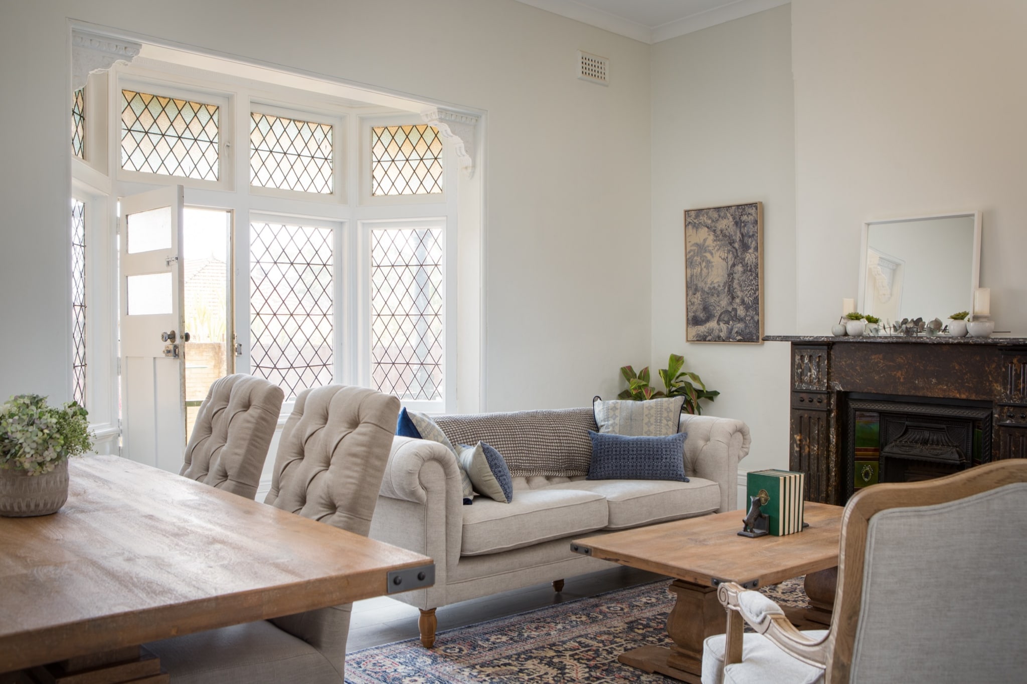 Property description
Whether you’re in Sydney for work or pleasure, this characterful apartment offers both convenience and elegance. Just around the corner from Strathfield Station, it’s easy to get to both the city and Olympic Park from here. There’s also private parking, which makes things simple if you have a car. The apartment is filled with light and features all the modern conveniences. The bathroom and kitchen are fully renovated, but if cooking isn’t your thing cheap and tasty restaurants abound nearby.

The space
This sun-filled apartment is perfect for business travellers and small groups. Laid out on one floor, it features a fully renovated kitchen and modern furniture, as well as access to a communal outdoor area. There are eight steps from street level to the property.