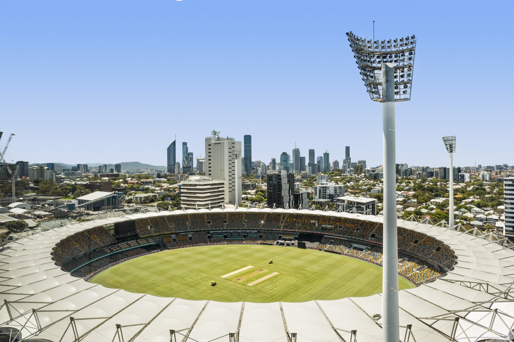 See The Gabba in a different way at this apartment that boasts one-of-a-kind stadium views amongst a cityscape backdrop. The views extend throughout this executive, well-styled property, which also features a modern living area and spacious bedrooms. Located in the Trafalgar Lane complex, you’ll have access to a range of amenities including a pool, spa, gym, and outdoor areas. With the Brisbane CBD only a short drive away, this Woolloongabba apartment makes a convenient base for any traveller.
The space
This is a well-styled apartment, appointed with modern decor and appliances throughout. The living area features an open-plan layout, with a sleek kitchen equipped with stainless steel appliances flows to a dining area. Sweeping views of The Gabba extend to the two bedrooms, and the apartment includes a study space in the living area, making it ideal for business travellers.
 
General
- Executive apartment with 2-bedrooms and 1-bathroom
- Stunning views of The Gabba and the city skyline
- Air conditioning and heating available
- On-site parking is available
- Wi-Fi is available
- Pool, spa and gym
- Self check-in
 
Bedroom & bathroom
- Bedroom 1: Queen bed with wardrobe space
- Bedroom 2: 2x Single beds with wardrobe space
- 1 separate bathroom
- Laundry facilities available
 
Kitchen
- Modern appliances
- Toaster, kettle, coffee machine and microwave available
- Oven and stovetop available
- Dishwasher available
 
Living Room
- TV available
- Couch
- 4-seater dining table
- Study area
 
Points of Interest
- Brisbane Cricket Ground (The Gabba) – a 1-minute walk away
- Gabba Central Shopping Centre – a 5-minute (350m) walk away
- Brisbane CBD – a 10-minute (3km) drive away
Local area description
Woolloongabba is home to The Gabba, Brisbane’s premier venue for cricket and AFL. It also boasts a lively dining scene comprising trendy bistros, international restaurants and heritage pubs. Shoppers will enjoy the various antique and vintage stores, while culture vultures have easy access to South Bank’s museums and the various attractions within the Brisbane CBD.
House rules
You are staying in a friendly and peaceful neighbourhood and we kindly ask you to respect the community and your surrounding neighbours. The following strict House Rules apply:
- No loud noise between 10 pm and 8 am
- No parties or antisocial behaviour
- No additional people are to access the property without our prior approval
- No pets are allowed in the property without approval
- No smoking is allowed at any times
- If you break something, please let us know
 
- To help protect all floor coverings do not wear any shoes inside the property
Please be aware that excessive noise such as amplified music, vocals or screaming or anti-social behaviour in the property or common areas can cause neighbours to complain to us, the Building Manager, Council Rangers or Police.
 
IMPORTANT: Any breach of the House Rules may lead to a $500 fine plus compensation for any cost/damage created and immediate eviction of the property.
 
Finally, when checking out, we kindly ask you for the following:
- Please leave all beds unmade
- Please clean up your dishes and put them away
- In case you have rearranged furniture, please put it back to the original location
- Please take out the rubbish and remember to use the right bins
- Please ensure all appliances, A/C and lights are off and doors and windows are closed
Interaction with guests
Welcome to MadeComfy! Our local team curates stays in exceptional Australian & New Zealand properties, ensuring style, comfort, and prime locations for discerning guests. We prioritise your needs to provide a memorable home-away-from-home experience. Explore our digital guidebooks for local recommendations, and don't hesitate to contact us throughout your stay. We're here to ensure your comfort – enjoy your stay with MadeComfy.
Notes
For your comfort, this property is prepared with professional-grade hotel-style linen, including a three-sheet setup, ensuring a fresh and hygienic sleep experience.
 
Extra Services:
- Early check-in: Our standard check-in is at 3 pm. To guarantee early access to the property we suggest booking the night before if available. Otherwise, early check-in is subject to availability from the night before at an additional cost.
- Late check-out: Our standard check-out is at 10 am. To guarantee a later check-out of the property we suggest booking an additional night if available. Otherwise, a late check-out is subject to availability from the night before to an additional cost.
- Baggage: For security reasons, we are unable to receive or to keep unattended baggage before check-in or after check-out
- We provide a small welcome amenity pack to get your stay started
- This booking is protected with coverage for lost baggage and emergency medical expenses, provided by Travel Support with claim upto 500 AUD (T&C Applies). For more details reach out to Guest Support team post booking.
Access description
- You’ll have access to the entire property when you stay here, so it will feel like your own home.
- The keys will be left in a lockbox onsite. We will send you the access code 3 days prior to your arrival through the booking portal.
- Enter the building, proceed to the elevators, scan the fob, and go to Level 18.
- The garage is located on Level 5; lot number R125. Car park access is via Trafalgar St. There is also additional parking for visitors.
Getting around
Public transport
There are plenty of bus stops on Stanley St, a short walk from the property, which can take you to Brisbane and surrounding areas.
 
Ride sharing
There are several taxi and ride-sharing options readily available throughout Brisbane.
 
Points of Interest
- Brisbane Cricket Ground (The Gabba) – a 1-minute walk away
- Gabba Central Shopping Centre – a 5-minute (350m) walk away
- Brisbane CBD – a 10-minute (3km) drive away
 
Airport access
The property is approximately a 15-minute drive from Brisbane Airport.
 
