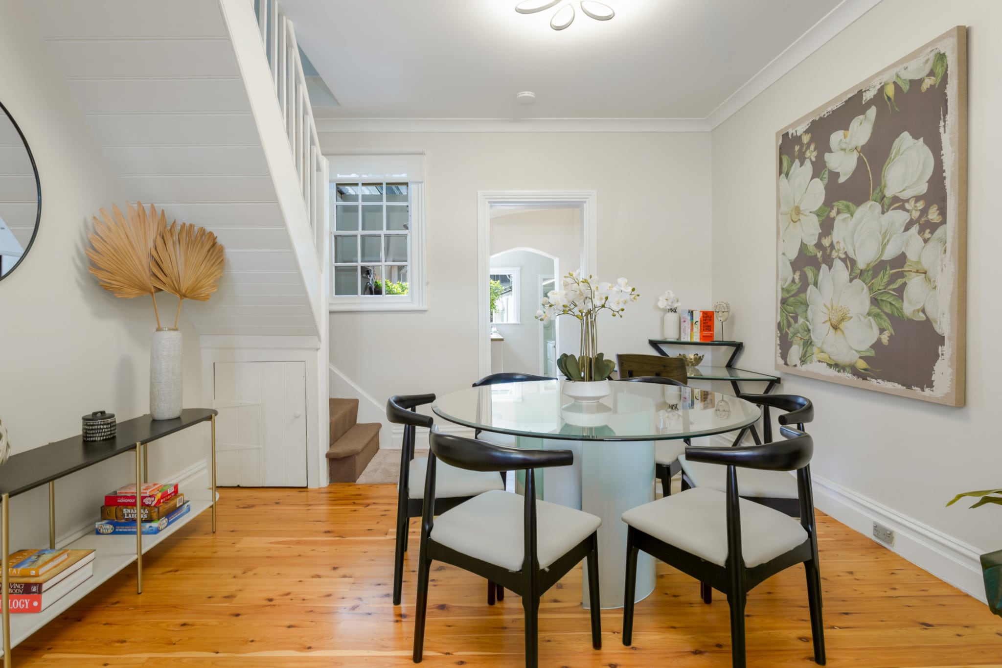 Immerse yourself in Sydney’s charming inner-city in this beautiful 2-bed terrace house with generous outdoor spaces. With its modern yet homely decor, this bright property offers both front and back yard seating areas as well as balconies to unwind on. Situated steps away from Harris Street, The Star and Darling Harbour, the property boasts unmatched proximity to numerous shops, cafes and reaustrants to indulge in. Perfect for those wanting an incredible Sydney trip, look no further.
The space
Meticulously designed, this bright terrace house offers a chic elevated style to contrast with the property's original facade. Featuring modern interior decor, cosy bedrooms, a sleek bathroom, a homely kitchen that's fully stocked with appliances, two private balconies, an open living design, a laundry room, a front yard deck and a back courtyard both with outdoor seating, this property offers an authentically charming inner-city base for your adventures.
 
General
- Chic 2-bedroom, 1-bathroom house.
- WIFI provided.
- Air conditioning and heating are available.
- Two cosy balconies with outdoor seating.
- Cosy front yard with outdoor seating.
- Generous backyard with outdoor seating.
 
Bedroom & bathroom
- Bedroom 1: 1x Queen Bed with balcony access upstairs
- Bedroom 2: 1x Double and 1x Single Beds (Bunk) with balcony access upstairs
- Sleek modern main bathroom on the ground floor
- Laundry room available (washer and dryer)
 
Kitchen
- Fully stocked with appliances.
- Toaster, kettle, coffee machine and microwave available
- Oven and electric stovetop available.
- Dishwasher available.
 
Living Room
- Plush couch, armchairs and a coffee table are available.
- SmartTV with free-to-air channels available.
- 6-seater dining table with a study nook.
 
Points of Interest
- Harris Street Shopping and Dining Strip– 1 minute (100m) walk away.
- The Star Complex (Casino, Theatre and Bars) - 5 minutes (400m) walk away.
- Harbourside Shopping Centre and Australian Maritime Museum - 8 minutes (550m) walk away.
 
Getting there
The property is approximately a 21-minute drive away from Sydney Airport.
Local area description
Pyrmont is a vibrant inner city suburb known for its industrial past and popular entertainment district. Peppered with parks and reserves, the suburb offers numerous harbourside walks that boast incredible views of the city. Best known as being the home to the Syndey Fish Markets and Star Casino complex, the area grants visitors a wide variety of cafe, shopping and dining experience to enjoy. With its close proximity to the City, Darling Harbour and Haymarket attractions, Pyrmont offers a truly unmatched location for your next visit.
House rules
You are staying in a friendly and peaceful neighbourhood and we kindly ask you to respect the community and your surrounding neighbours. The following strict House Rules apply:
 
- No loud noise between 10 pm and 8 am
- No parties or antisocial behaviour
- No additional people are to access the property without our prior approval
- No pets are allowed in the property without approval
- No smoking is allowed at any times
- If you break something, please let us know
- To help protect all floor coverings do not wear any shoes inside the property
 
Please be aware that excessive noise such as amplified music, vocals or screaming or anti-social behaviour in the property or common areas can cause neighbours to complain to us, the Building Manager, Council Rangers or Police.
 
- There are stairs on the property
 
IMPORTANT: Any breach of the House Rules may lead to a $500 fine plus compensation for any cost/damage created and immediate eviction of the property.
 
Finally, when checking out, we kindly ask you for the following:
 
- Please leave all beds unmade
- Please clean up your dishes and put them away
- In case you have rearranged furniture, please put it back to the original location
- Please take out the rubbish and remember to use the right bins
- Please ensure all appliances, A/C and lights are off and doors and windows are closed
Interaction with guests
Welcome to MadeComfy! Our local team curates stays in exceptional Australian & New Zealand properties, ensuring style, comfort, and prime locations for discerning guests. We prioritise your needs to provide a memorable home-away-from-home experience. Explore our digital guidebooks for local recommendations, and don't hesitate to contact us throughout your stay. We're here to ensure your comfort – enjoy your stay with MadeComfy.
Notes
For your comfort, this property is prepared with professional-grade hotel-style linen, including a three-sheet setup, ensuring a fresh and hygienic sleep experience.
 
Other things to note
- There is no on-site parking available and all street parking is limited to 1-2P.
- Pets allowed upon approved requests, additional fees apply
 
Extra Services:
- Early check-in: Our standard check-in is at 3 pm. To guarantee early access to the property we suggest booking the night before if available. Otherwise, early check-in is subject to availability from the night before at an additional cost.
- Late check-out: Our standard check-out is at 10 am. To guarantee a later check-out of the property we suggest booking an additional night if available. Otherwise, a late check-out is subject to availability from the night before to an additional cost.
- Baggage: For security reasons, we are unable to receive or to keep unattended baggage before check-in or after check-out
- We provide a small welcome amenity pack to get your stay started
- There are stairs on the property
- This booking is protected with coverage for lost baggage and emergency medical expenses, provided by Travel Support with claim upto 500 AUD (T&C Applies). For more details reach out to Guest Support team post booking.
Access description
You’ll have access to the entire property when you stay here, so it will feel like your own home.
Getting around
Public transport
The property is within walking distance of two bus and light rail stops. On Harris St, you’ll find bus stops operating trips to Central Station, Bondi Jct. Interchange, The Star and Parramatta. Meanwhile, the Convention and Wentworth Park light rail stops operate routes to and from Dulwich Hill / Central Station.
 
Ride sharing
There are plenty of taxi and ride-sharing options readily available throughout Sydney.
 
Points of Interest
- Harris Street Shopping and Dining Strip– 1 minute (100m) walk away.
- The Star Complex (Casino, Theatre and Bars) - 5 minutes (400m) walk away.
- Harbourside Shopping Centre and Australian Maritime Museum - 8 minutes (550m) walk away.
 
Getting there
The property is approximately a 21-minute drive away from Sydney Airport.