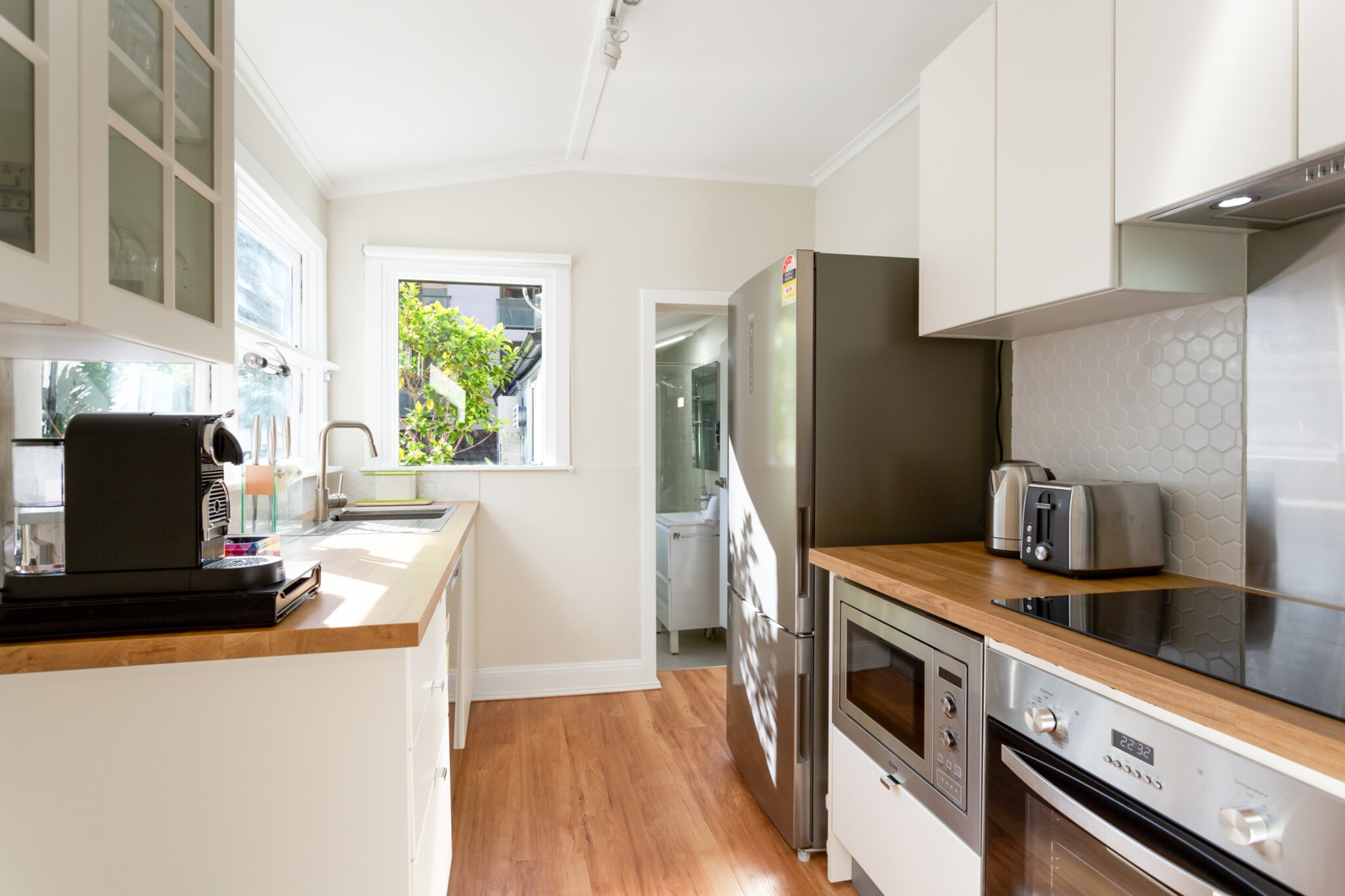 Bed Linen, Desk, Hot Water, Wardrobe, Living room(TV, dining table, seating area), Kitchen(stove, electric kettle, toaster, coffee machine, oven, microwave, dishwasher, fridge, dishes and cutlery), bedroom(Queen Bed), bedroom(bunk bed), bathroom(shower, washbasin, toilet, hairdryer, Towels/Sheets (Incl.), shampoo, Essentials), First Aid, tumble dryer, washing machine, balcony or terrace, heating, air conditioning, iron, Dedicated workspace, Carbon monoxide detector, Room-darkening shades, Wine glasses