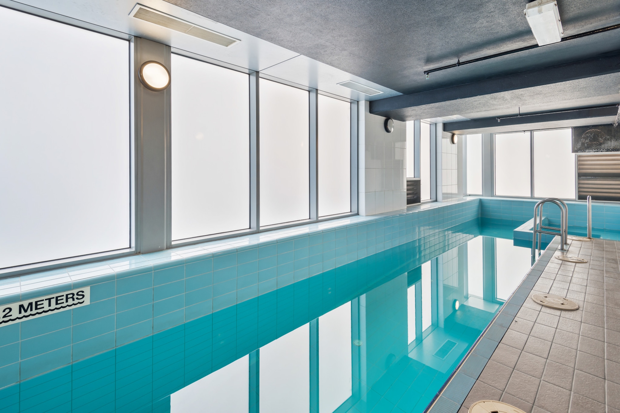 The space
This is a well-lit, executive apartment that makes a convenient base for any traveller. It features a compact yet fully-equipped kitchenette for your needs, and you can enjoy the views from the open-plan living and dining area. The views of the city further extend to the master bedroom, with another comfortable bedroom featuring a queen bed in the apartment.

General
- Entire 2-bedroom, 2-bathroom apartment
- Private balcony with BBQ
- Wi-Fi provided

Bedroom & bathroom
- Bedroom 1: 1x Queen bed with wardrobe space
- Bedroom 2: 1x Queen bed
- 2 bathrooms
- Laundry facilities available with washer

Kitchen
- Modern appliances
- Kettle and microwave available
- Oven and stovetop available
- Dishwasher available

Living room
- TV with free-to-air and streaming options
- Air-conditioning
- Couch
- 2-seater dining table

Points of Interest
- Melbourne Museum – a 10-minute (700m) walk away
- Emporium Melbourne – an 8-minute (600m) walk away
- State Library of Victoria – a 5-minute (400m) walk away

Airport Access
The property is located a 25-minute drive from Melbourne Airport.
Local area description
Situated in Melbourne's bustling heart, this property offers a vibrant city lifestyle. Enjoy world-class art at the nearby National Gallery of Victoria or unwind at the tranquil Royal Botanical Gardens. The iconic Flinders Street Station and Queen Victoria Market are just around the corner, offering excellent transport links and shopping opportunities. Don't miss the panoramic city views from the Eureka Skydeck. Experience the best of Melbourne living here.
House rules
You are staying in a friendly and peaceful neighbourhood and we kindly ask you to respect the community and your surrounding neighbours. The following strict House Rules apply:

- No loud noise between 10 pm and 8 am
- No parties or antisocial behaviour
- No additional people are to access the property without our prior approval
- No pets are allowed in the property without approval
- No smoking is allowed at any times
- If you break something, please let us know
- To help protect all floor coverings do not wear any shoes inside the property

Please be aware that excessive noise such as amplified music, vocals or screaming or anti-social behaviour in the property or common areas can cause neighbours to complain to us, the Building Manager, Council Rangers or Police.

IMPORTANT: Any breach of the House Rules may lead to a $500 fine plus compensation for any cost/damage created and immediate eviction of the property.

Finally, when checking out, we kindly ask you for the following:

- Please leave all beds unmade
- Please clean up your dishes and put them away
- In case you have rearranged furniture, please put it back to the original location
- Please take out the rubbish and remember to use the right bins
- Please ensure all appliances, A/C and lights are off and doors and windows are closed
Interaction with guests
Welcome to MadeComfy! Our local team curates stays in exceptional Australian & New Zealand properties, ensuring style, comfort, and prime locations for discerning guests. We prioritise your needs to provide a memorable home-away-from-home experience. Explore our digital guidebooks for local recommendations, and don't hesitate to contact us throughout your stay. We're here to ensure your comfort – enjoy your stay with MadeComfy.
Notes
- For your comfort, this property is prepared with professional-grade hotel-style linen, including a three-sheet setup, ensuring a fresh and hygienic sleep experience.
- Air conditioner is available in the living room only.
- There is no parking available at the property.

Extra Services:
- Early check-in: Our standard check-in is at 3 pm. To guarantee early access to the property we suggest booking the night before if available. Otherwise, early check-in is subject to availability from the night before at an additional cost.
- Late check-out: Our standard check-out is at 10 am. To guarantee a later check-out of the property we suggest booking an additional night if available. Otherwise, a late check-out is subject to availability from the night before to an additional cost.
- Baggage: For security reasons, we are unable to receive or to keep unattended baggage before check-in or after check-out
- We provide a small welcome amenity pack to get your stay started
- This booking is protected with coverage for lost baggage and emergency medical expenses, provided by Travel Support with claim upto 500 AUD (T&C Applies). For more details reach out to Guest Support team post booking.
Access description
- You will need to collect keys from a convenience store close by.
- Key collection is offsite, 350 meters from the property and not available 24/7. Further details will be provided 3 days before check-in if your booking is successfully reserved.
Getting around
Public transport