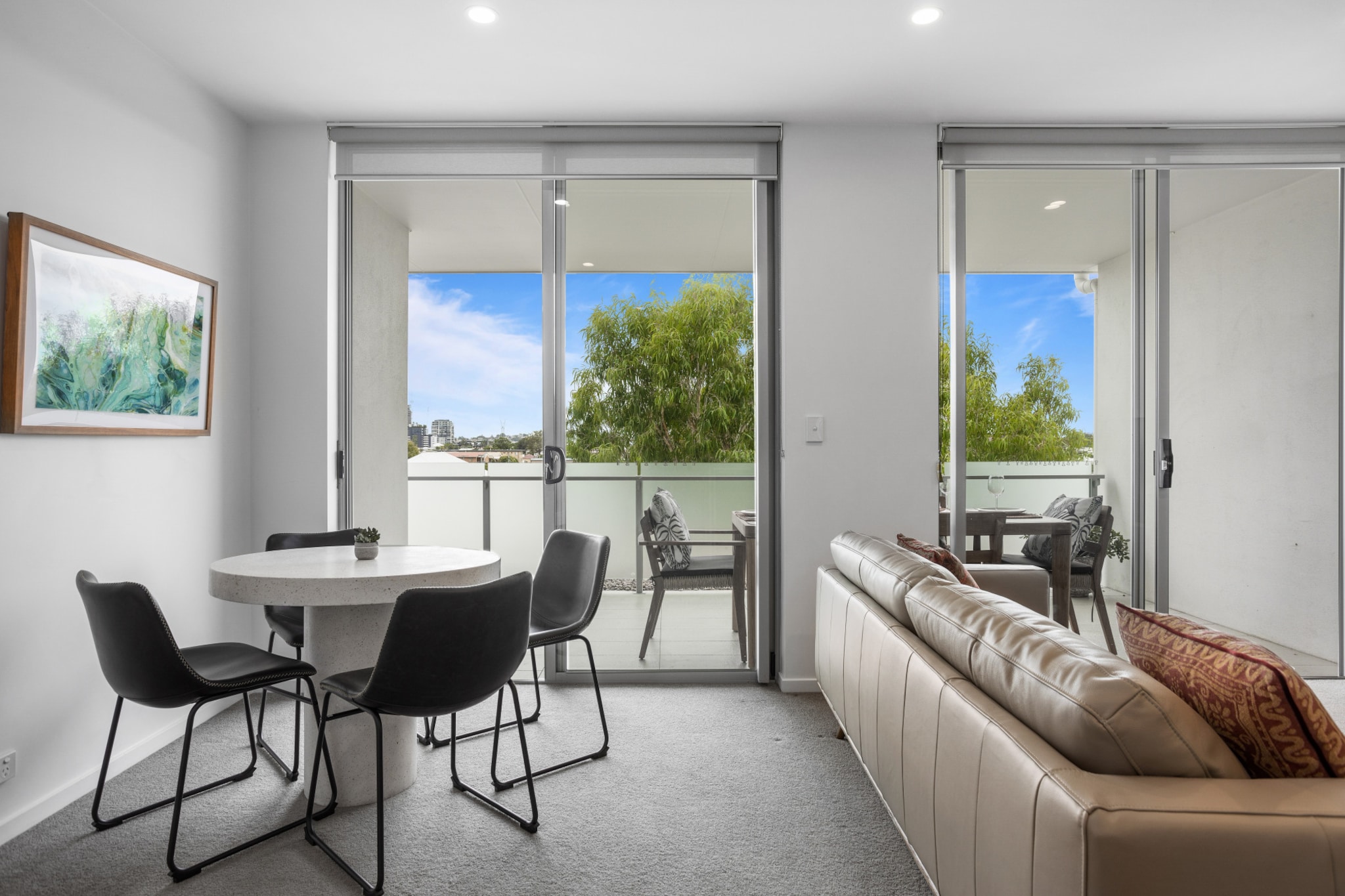 Immerse yourself in the Brisbane lifestyle in this sleek 2-bed apartment with leafy views from your own private balcony. Situated within walking distance to local shops, the Howard Smith Wharves and the vibrant Fortitude Valley entertainment precinct, experience all Brisbane's inner-north has to offer. With sharp modern interiors and access to a rooftop BBQ area, this property is ideal for those looking to truly submerge themselves in the city's bustling atmosphere.
The space
Modernly designed this beautifully furnished apartment features an abundance of natural light that brightens up the entire property. With charming views, rooftop BBQ area access, a fully stocked modern kitchen, great outdoor seating and two cosy bedrooms with balcony access, appreciate the simplicity of this sleek apartment.
 
General
- Bright 2-bedroom, 2-bathroom apartment
- Wi-Fi is provided
- BBQ area access
- Air conditioning and heating is available
- Balcony with outdoor seating and dining
- A rooftop common entertainment area is available
- Self check-in
 
Bedroom & bathroom
- Bedroom 1: 1x Queen Bed with walk-in robe, ensuite and balcony access
- Bedroom 2: 1x Queen Bed with balcony access
- Modern main bathroom
- Laundry unit available
 
Kitchen
- Fully stocked with modern appliances
- Kettle and toaster available
- Oven and stovetop available
- Dishwasher available
- 2-seater countertop stools available
 
Living Room
- SmartTV with streaming options available
- Leather couch and a coffee table are available
- 4-seater stone dining table
 
Points of Interest
Institute of Modern Art and Judith Wright Arts Centre - 6 minutes (450m) walk away
Howard Smith Wharves - 3 minutes (50m) walk away
Fortitude Valley Entertainment Precinct and Music Hall - 10 minutes (800m) walk away
James Street Precinct - 7 minutes (550m) walk away
Local area description
New Farm is a breezy Brisbane suburb known for its namesake park and for being a leafy residential area. Set along the northern shores of the Brisbane River enjoy the numerous riverside BBQ spots, picnic areas and the aforementioned Riverwalk. With a vibrant cafe and restaurant scene centred around Brunswick St, New Farm offers quaint alternatives to the bustling city food scene. Home to the Brisbane Powerhouse and Merthyr Village Shopping Centre, the suburb offers a number of events year round that keeps the suburb feeling thriving and fresh.
House rules
You are staying in a friendly and peaceful neighbourhood and we kindly ask you to respect the community and your surrounding neighbours. The following strict House Rules apply:
- No loud noise between 10 pm and 8 am
- No parties or antisocial behaviour
- No additional people are to access the property without our prior approval
- No pets are allowed in the property without approval
- No smoking is allowed at any times
- If you break something, please let us know
 
- To help protect all floor coverings do not wear any shoes inside the property
 
Please be aware that excessive noise such as amplified music, vocals or screaming or anti-social behaviour in the property or common areas can cause neighbours to complain to us, the Building Manager, Council Rangers or Police.
 
IMPORTANT: Any breach of the House Rules may lead to a $500 fine plus compensation for any cost/damage created and immediate eviction of the property.
 
Finally, when checking out, we kindly ask you for the following:
- Please leave all beds unmade
- Please clean up your dishes and put them away
- In case you have rearranged furniture, please put it back to the original location
- Please take out the rubbish and remember to use the right bins
- Please ensure all appliances, A/C and lights are off and doors and windows are closed
Interaction with guests
Welcome to MadeComfy! Our local team curates stays in exceptional Australian & New Zealand properties, ensuring style, comfort, and prime locations for discerning guests. We prioritise your needs to provide a memorable home-away-from-home experience. Explore our digital guidebooks for local recommendations, and don't hesitate to contact us throughout your stay. We're here to ensure your comfort – enjoy your stay with MadeComfy.
Notes
- For your comfort, this property is prepared with professional-grade hotel-style linen, including a three-sheet setup, ensuring a fresh and hygienic sleep experience.
- Close to public transport.
- Free visitor parking spots in the carpark is available.
- Please keep noise level to a minimum between 10pm and 8am for neighbours. Excessive noise could lead to an on-the-spot AUD500 fine and/or eviction from the property.
- The only on-site parking available is visitor parking in the car park. There's a parking permit lanyard available, though the street has a 4pm-6pm clearway. Free parking on Kent Street available.
 
Extra Services:
- Early check-in: Our standard check-in is at 3 pm. To guarantee early access to the property we suggest booking the night before if available. Otherwise, early check-in is subject to availability from the night before at an additional cost.
- Late check-out: Our standard check-out is at 10 am. To guarantee a later check-out of the property we suggest booking an additional night if available. Otherwise, a late check-out is subject to availability from the night before to an additional cost.
- Baggage: For security reasons, we are unable to receive or to keep unattended baggage before check-in or after check-out
- We provide a small welcome amenity pack to get your stay started
- This booking is protected with coverage for lost baggage and emergency medical expenses, provided by Travel Support with claim upto 500 AUD (T&C Applies). For more details reach out to Guest Support team post booking.
Access description
- Key collection is offsite, 850m from the property and not available 24/7. Further details will be provided 3 days before check-in if your booking is successfully reserved.
Getting around
Public transport
There are two bus stops located on the same road as the property operating a route to Commercial Rd (Vernon Tce), New Farm (Mountford Rd), West End Ferry and Fairfield Gardens.
 
Ride sharing
There are plenty of taxi and ride-sharing options readily available throughout Brisbane.
 
Points of Interest
Institute of Modern Art and Judith Wright Arts Centre - 6 minutes (450m) walk away.
Howard Smith Wharves - 3 minutes (250m) walk away.
Fortitude Valley Entertainment Precinct and Music Hall - 10 minutes (800m) walk away.
James Street Precinct - 7 minutes (550m) walk away.
 
Getting there
The property is approximately an 18-minute drive from Brisbane Airport.