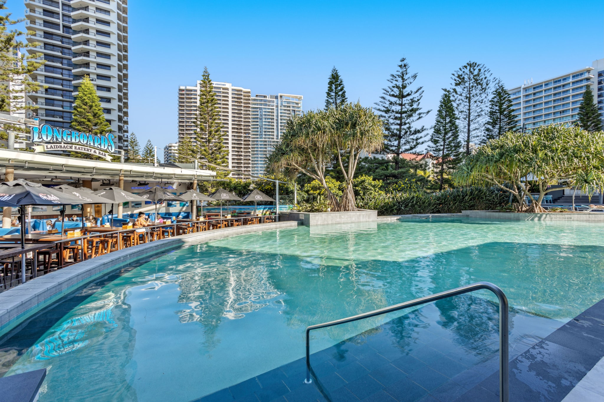 Appreciate the stunning Surfers Paradise in this gorgeous 2 bedroom apartment with ocean views and a pool. Situated in the heart of this bustling seaside resort town, enjoy the numerous shops, cafes, restaurants and the beach all within walking distance of the property. With on-site parking, gym and sauna facilities also available, this apartment is perfect for those looking for a truly incredible trip.
The space
Meticulously designed this incredible apartment offers chic interior decor that accentuates the stunning views and natural light that the property boasts. With 2 comfortable bedrooms, an elegant kitchen, countertop stool seating, modern appliances, sleek bathroom, an open living design and an enclosed balcony with a dining table, this property is a perfect summer destination.
 
General
- Modern 2-bedroom, 1-bathroom unit
- Close to public transport
- Wi-Fi is available
- On-site parking available
- Air conditioner and heater available
- Incredible ocean views from the living room
- Private enclosed balcony with seating and dining table
- Pool, gym and sauna facilities are available for communal use
- Self check-in
 
Bedroom & bathroom
- Bedroom 1: 1x Queen Bed with an ensuite
- Bedroom 2: 1x Double Bed
- Sleek modern bathroom
- Laundry room available - washer and dryer
 
Kitchen
- Fully stocked upstairs kitchen with appliances, cookware and utensils
- Kettle, toaster, coffee machine and microwave available
- Oven and gas stovetop available
- Dishwasher available
- 4-seater countertop stools
 
Living Room
- Plush couches and coffee table available
- TV with free-to-air channels available
- 6-seater dining table