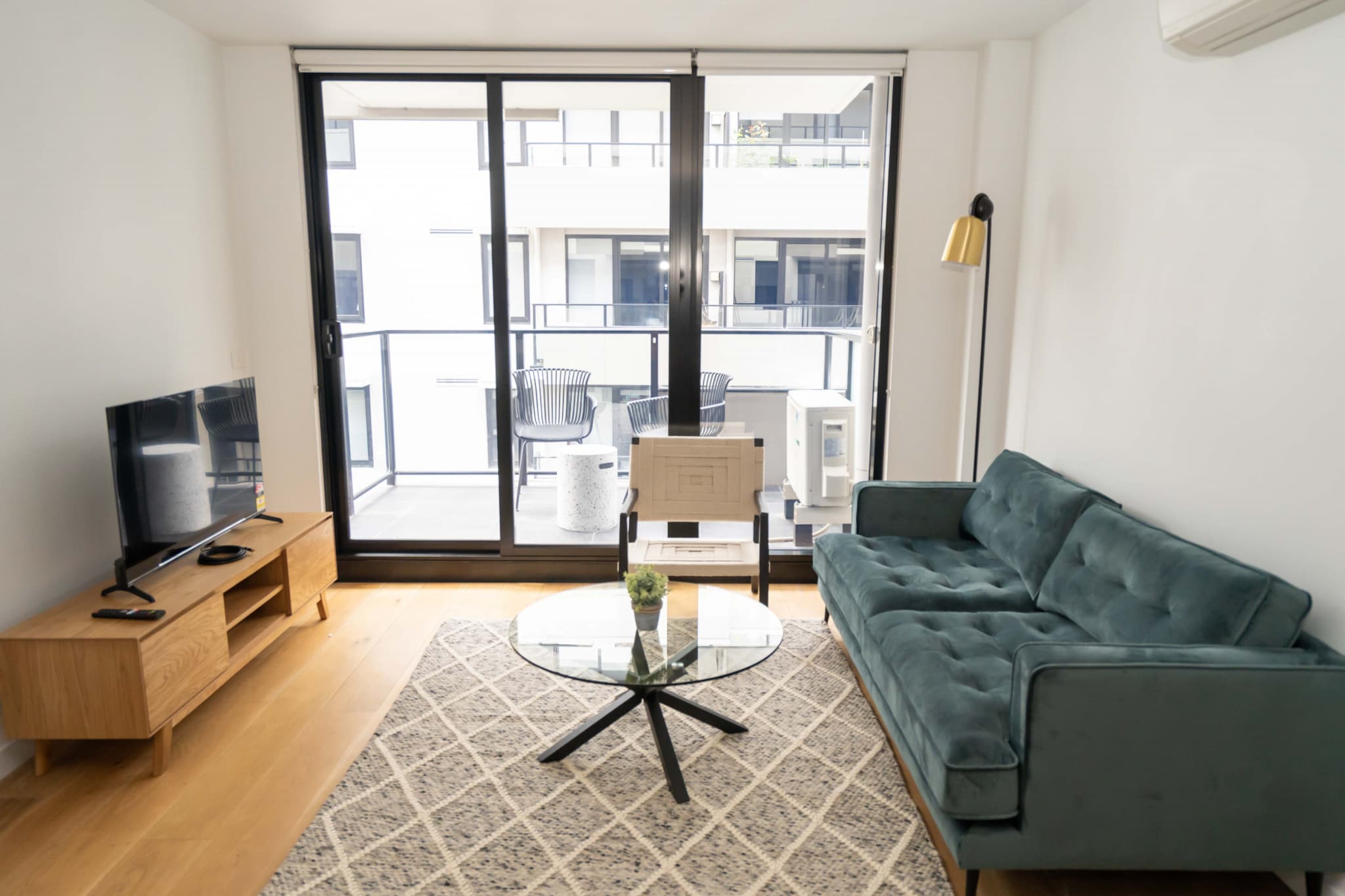 Experience the vibrant atmosphere of Melbourne inner-city with this idyllic 1-bed apartment near the popular Lygon and Nicholson shopping streets. Offering sleek interiors and a charming balcony with outdoor seating, the property also boasts access to an on-site pool, gym, spa facilities and a communal rooftop terrace with a cinema area. Situated a short walk from local cafes, shops, bars and restaurants this apartment is perfect for couples looking to relish in Melbourne’s inner-city scenes.
The space
This chic apartment offers charming interiors creating a warm and welcoming atmosphere. With an open-plan living area, an elegant kitchen, modern appliances, a sleek bathroom, stylish decor, a comfy bedroom and a private balcony with outdoor seating. This pristine property is a quiet and pristine escape from the busy Melbourne city lifestyle.
 
General
- Chic 1-bedroom, 1-bathroom apartment.
- On-site parking available.
- Air conditioner and heater available in the lounge.
- Sleek interiors with modern decor.
- WIFI provided.
- Private balcony with outdoor seating available.
- On-site pool, gym and rooftop terrace.
 
Bedroom & bathroom
- Bedroom 1: 1x Queen Bed.
- Portable fan and heater in the bedroom.
- Sleek modern bathroom.
- Laundry unit with washer and dryer.
 
Kitchen
- Fully stocked with cookware, utensils and cutlery.
- Toaster, kettle, coffee machine and microwave available.
- Oven and electrical stove top available.
- Dishwasher available.
 
Living Room
- Plush couch, armchair and a coffee table available.
- TV with free-to-air channels and streaming options available.
- 4-seater dining table available.
- Study desk
 
Points of Interest
- Nicholson St Shopping and Dining Strip - 2 minutes (160m) walk away.
- Lygon St Shopping and Dining Strip - 6 minutes (500m) walk away.
- Edinburgh Gardens - 5 minutes (1.4km) drive away.
 
Getting there
The property is roughly a 25-minute drive from Melbourne Airport.
Local area description
East Brunswick is a vibrant Melbourne suburb boasting a central inner city location and eclectic atmosphere. Boasting a thriving dining and bar scene, the suburb offers a wide array of venues and delicacies to indulge yourself in. Bursting with boutique stores, artistic workshops, famous dining venues and more, East Brunswick offers a truly welcoming and unique vibe.