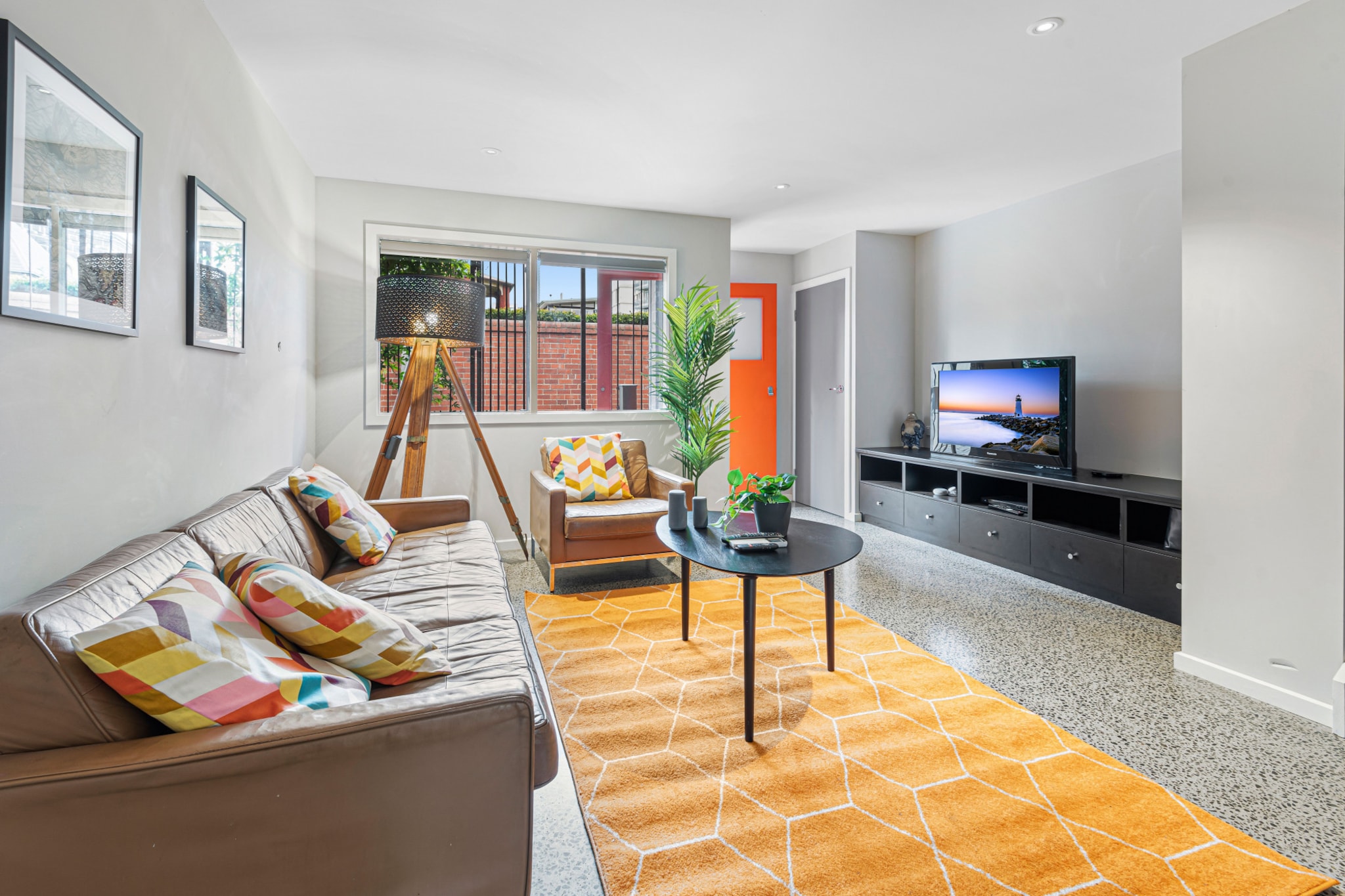 Located in sunny Bayside Port Melbourne, this two-storey townhouse is only moments away from Port Melbourne beach and Princes Pier and assures light-filled, indoor-outdoor living. Enjoy bright open spaces and spacious interiors, complete with heating and cooling, laundry, WI-FI, and a lovely courtyard. Coupled with the nearby light rail to Melbourne city and Bay Street shopping strip, enjoy ultimate comfort, convenience and modern refinement.
The space
Conveniently located close to multiple attractions and amenities, this property has everything you need for a comfortable stay. You’ll have access to two bedrooms, a full laundry, a kitchen and all essential toiletries and linen will be provided for your convenience. Whether you intend to spend your time shopping, working in Melbourne, at the beach or in the comfort of a sunbathed townhouse, your options are limitless from this place.
 
General
- 2 bedroom townhouse with bathroom
- Spacious, modern and bright interiors
- Sunny courtyard with outdoor furniture
- Air conditioning and heating available
- Wi-Fi provided
- Laundry unit with washer and dryer
 
Bedroom & Bathroom
- 2 queen bedrooms with blackout blinds
- Spacious bathroom with travel essentials, towels and hairdryer provided
 
Kitchen
- Fully equipped with cookware, utensils and cutlery
- Toaster and coffee machine
- Oven and electric stovetop
- Microwave
 
Living / Dining Room
- Comfortable lounge and dining setting for 4
- TV available with free-to-air options
- Air conditioning available
 
Points of Interest
- 2 min drive, 8 min walk to Pier Port Melbourne and Port Melbourne Beach
- 3 min drive, 10 min walk to Coles Port Melbourne
- 3 min drive, 14 min walk to Princes Pier and New beach
- 6 min drive, 29 min walk to South Melbourne Market
- 16 min drive to Melbourne CBD
House rules
You are staying in a friendly and peaceful neighbourhood and we kindly ask you to respect the community and your surrounding neighbours. The following strict House Rules apply:
 
- No loud noise between 10 pm and 8 am
- No parties or antisocial behaviour
- No additional people are to access the property without our prior approval
- No pets are allowed in the property without approval
- No smoking is allowed at any times
- If you break something, please let us know
 
- To help protect all floor coverings do not wear any shoes inside the property
 
Please be aware that excessive noise such as amplified music, vocals or screaming or anti-social behaviour in the property or common areas can cause neighbours to complain to us, the Building Manager, Council Rangers or Police.
 
IMPORTANT: Any breach of the House Rules may lead to a $500 fine plus compensation for any cost/damage created and immediate eviction of the property.
 
Finally, when checking out, we kindly ask you for the following:
 
- Please leave all beds unmade
- Please clean up your dishes and put them away
- In case you have rearranged furniture, please put it back to the original location
- Please take out the rubbish and remember to use the right bins
- Please ensure all appliances, A/C and lights are off and doors and windows are closed
Interaction with guests
Welcome to MadeComfy! Our local team curates stays in exceptional Australian & New Zealand properties, ensuring style, comfort, and prime locations for discerning guests. We prioritise your needs to provide a memorable home-away-from-home experience. Explore our digital guidebooks for local recommendations, and don't hesitate to contact us throughout your stay. We're here to ensure your comfort – enjoy your stay with MadeComfy.
Notes
- For your comfort, this property is prepared with professional-grade hotel-style linen, including a three-sheet setup, ensuring a fresh and hygienic sleep experience.
- Please keep noise level to a minimum between 10pm and 8am for neighbours. Excessive noise could lead to an on-the-spot AUD500 fine and/or eviction from the property.
- There are stairs at the property.
- Unlimited street parking.
 
Extra Services:
- Early check-in: Our standard check-in is at 3 pm. To guarantee early access to the property we suggest booking the night before if available. Otherwise, early check-in is subject to availability from the night before at an additional cost.
- Late check-out: Our standard check-out is at 10 am. To guarantee a later check-out of the property we suggest booking an additional night if available. Otherwise, a late check-out is subject to availability from the night before to an additional cost.
- Baggage: For security reasons, we are unable to receive or to keep unattended baggage before check-in or after check-out
- We provide a small welcome amenity pack to get your stay started
- Cleaning services are available during your stay for an additional cost. Inform us and we'll organise it for you
- This booking is protected with coverage for lost baggage and emergency medical expenses, provided by Travel Support with claim upto 500 AUD (T&C Applies). For more details reach out to Guest Support team post booking.
Access description
You’ll have access to the entire property when you stay here, so it will feel like your own home.
Getting around
Public transport
Public transport is a breeze with Graham St/Light Rail (Port Melbourne) just a 6 min walk away. The city is also only a ten minute tram ride away. Check out the TripGo app for transport timetables.
 
Ride sharing
We highly recommend using ride-sharing services: For first time users, download the Uber app for more information.
 
Points of Interest
- 2 min drive, 8 min walk to Pier Port Melbourne and Port Melbourne Beach
- 3 min drive, 10 min walk to Coles Port Melbourne
- 3 min drive, 14 min walk to Princes Pier and New beach
- 6 min drive, 29 min walk to South Melbourne Market
- 16 min drive to Melbourne CBD
 
Getting there
The property is approximately a 25 min drive from Tullamarine Airport and 36 min drive from Avalon Airport.
