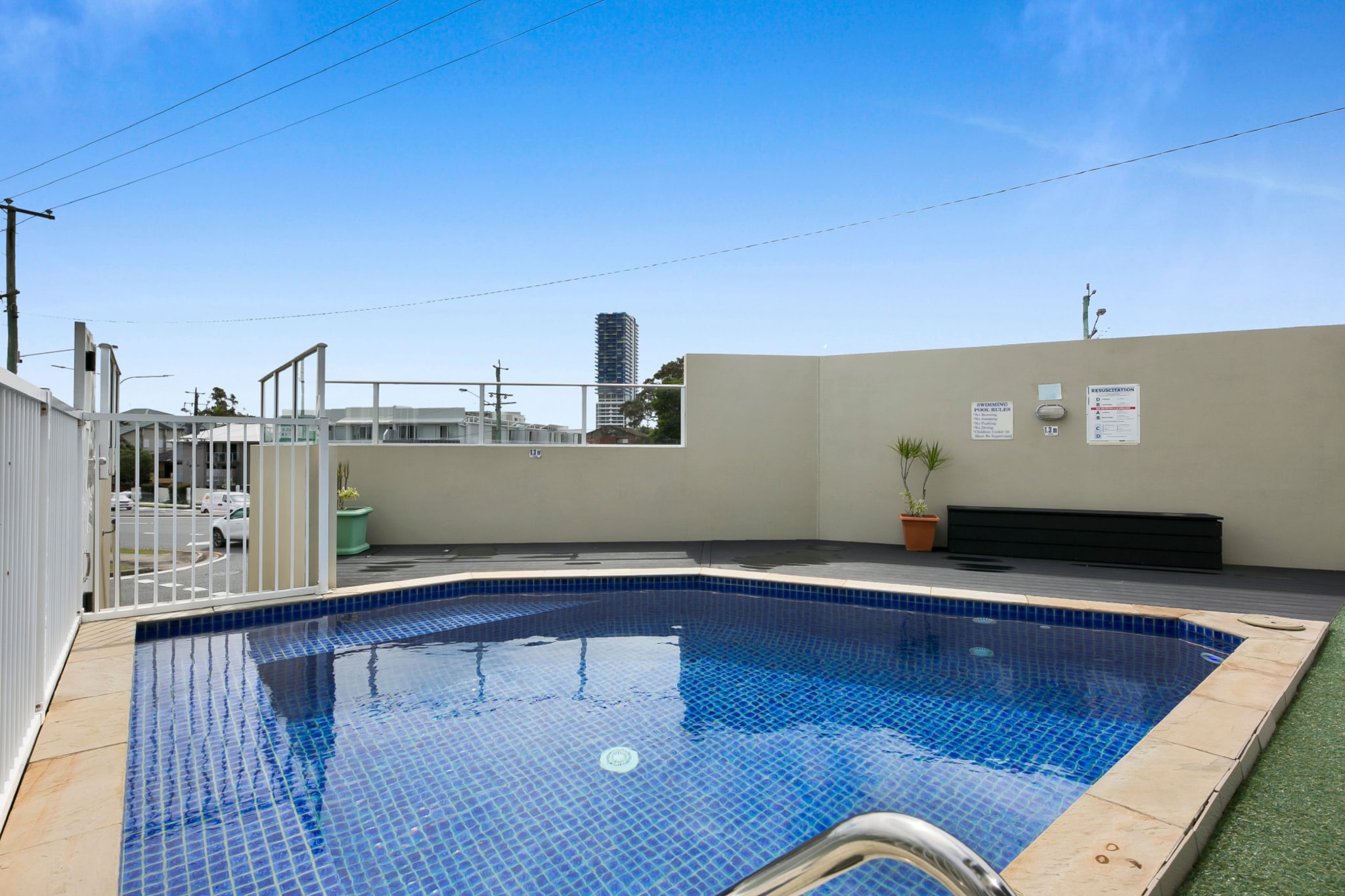 Appreciate the sunny Gold Coast in this sleek apartment with a pool and rooftop terrace. Offering a cosy design and chic decor this modern property is the ideal escape for any curious traveller. Situated near cafes, shops, parks and the popular Gold Coast Chinatown explore the vibrant local attractions all located on your front doorstep. With its private balcony, amenities and prime location, this property is the perfect stay for those wanting an elegant and convenient how away from home.
The space
Modestly designed, this cosy apartment features chic decor that accentuates the charmingly welcoming atmosphere. Featuring an open living design, a sleek kitchen, modern appliances, a glossy bathroom, a comfortable bedroom, an additional sofa bed and a private balcony with outdoor seating. Settle into this truly chic apartment, ripe with holiday potential.
 
General
- Chic 1-bedroom, 1-bathroom apartment
- On-site parking is available for 1 vehicle
- Air conditioner available
- Laundry facilities available - washer and dryer
- Private balcony with outdoor seating available
- Pool and communal rooftop BBQ facilities are available
- Wi-Fi is available
- Self check-in
 
Bedroom & Bathroom
- Bedroom 1: 1x Queen Bed with an ensuite
- Additional Sofa Bed available
- Sleek modern bathroom
- Travel essentials, towels and hairdryer provided
 
Kitchen
- Fully equipped with cookware, utensils and cutlery
- Kettle, toaster, coffee machine and microwave available
- Oven and electric stovetop available
 
Living Room
- Plush couch with a coffee table available
- TV with free-to-air and streaming options available
- 4-seater dining table available
 
Points of Interest
- Chinatown Gold Coast - 3 minutes (900m) drive away
- Broadwater Parklands - 5 minutes (1.2km) drive away
- Australia Fair Shopping Centre - 5 minutes (1.3km) drive away
Local area description
Southport is a rich and vibrant suburb of the Gold Coast set along the banks of the Nerang River, just inland from Surfers Paradise. Boasting an extensive selection of cafes and restaurants to indulge in the suburb offers innumerable venues to enjoy the riverside views. Home to numerous attractions Southport is also home to a waterpark, parklands, sea diving sites and the famous Australia Fair Shopping Centre. With its broad range of attractions and experiences, this central suburb is the ideal location for a memorable trip.
House rules
You are staying in a friendly and peaceful neighbourhood and we kindly ask you to respect the community and your surrounding neighbours. The following strict House Rules apply:
- No loud noise between 10 pm and 8 am
- No parties or antisocial behaviour
- No additional people are to access the property without our prior approval
- No pets are allowed in the property without approval
- No smoking is allowed at any times
- If you break something, please let us know
 
- To help protect all floor coverings do not wear any shoes inside the property
 
Please be aware that excessive noise such as amplified music, vocals or screaming or anti-social behaviour in the property or common areas can cause neighbours to complain to us, the Building Manager, Council Rangers or Police.
 
IMPORTANT: Any breach of the House Rules may lead to a $500 fine plus compensation for any cost/damage created and immediate eviction of the property.
 
Finally, when checking out, we kindly ask you for the following:
- Please leave all beds unmade
- Please clean up your dishes and put them away
- In case you have rearranged furniture, please put it back to the original location
- Please take out the rubbish and remember to use the right bins
- Please ensure all appliances, A/C and lights are off and doors and windows are closed.
Interaction with guests
Welcome to MadeComfy! Our local team curates stays in exceptional Australian & New Zealand properties, ensuring style, comfort, and prime locations for discerning guests. We prioritise your needs to provide a memorable home-away-from-home experience. Explore our digital guidebooks for local recommendations, and don't hesitate to contact us throughout your stay. We're here to ensure your comfort – enjoy your stay with MadeComfy.
Notes
- For your comfort, this property is prepared with professional-grade hotel-style linen, including a three-sheet setup, ensuring a fresh and hygienic sleep experience.
- To access the on-site parking, go up the driveway and ahead will be the declining driveway, head down scanning the fob on the reader on the right.
- Secure on-site garage parking available for 1 vehicle.
 
Extra Services:
- Early check-in: Our standard check-in is at 3 pm. To guarantee early access to the property we suggest booking the night before if available. Otherwise, early check-in is subject to availability from the night before at an additional cost.
- Late check-out: Our standard check-out is at 10 am. To guarantee a later check-out of the property we suggest booking an additional night if available. Otherwise, a late check-out is subject to availability from the night before to an additional cost.
- Baggage: For security reasons, we are unable to receive or to keep unattended baggage before check-in or after check-out
- We provide a small welcome amenity pack to get your stay started
- This booking is protected with coverage for lost baggage and emergency medical expenses, provided by Travel Support with claim upto 500 AUD (T&C Applies). For more details reach out to Guest Support team post booking.
Access description
- The keys will be left in a lockbox onsite. We will send you the access code 3 days prior to your arrival through the booking portal.
- You’ll have access to the entire property when you stay here, so it will feel like your own home.
Getting around
Public transport
Property is located a block away from bus stops on Johnston St and North St operating routes to Paradise Point, Southport and Helensvale Station. Meanwhile, the Nerang St light rail station is situated 800m from the property and operates routes to Helensvale and Broadbeach South.
 
Ride sharing
There are plenty of taxi and ride-sharing options readily available throughout the Gold Coast.
 
Points of Interest
- Chinatown Gold Coast - 3 minutes (900m) drive away.
- Broadwater Parklands - 5 minutes (1.2km) drive away.
- Australia Fair Shopping Centre - 5 minutes (1.3km) drive away.
 
Getting there
Property is roughly a 40-minute drive from Gold Coast Airport or a 1-hour drive from Brisbane’s CBD.