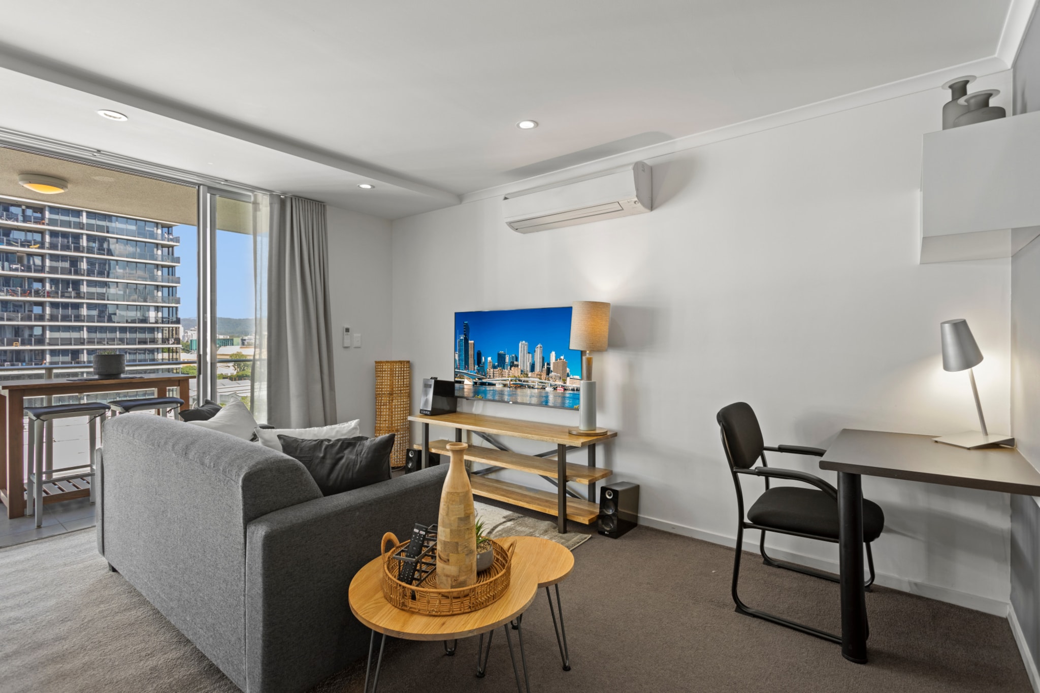 Indulge in the vibrant local atmosphere with this chic 2-bed apartment in South Brisbane's heart. Offering sleek interiors this modern property boasts a private balcony with outdoor seating, a BBQ and views to enjoy. Situated atop a cafe, the property offers close proximity to shops, restaurants, pubs, and the iconic South Brisbane entertainment and arts precinct. Featuring on-site gym and pool facilities, this property is the ideal base for those wanting to explore all Brisbane has to offer.
The space
Intelligently designed this pristine apartment offers chic decor, charming views and an abundance of natural light to appreciate. Featuring an open living plan, a sleek kitchen, modern appliances, elegant bathrooms, bedrooms with ensuites, a study nook, a plush living room sofa, a smartTV and a balcony with outdoor seating, a BBQ and views. This property is the perfect Brisbane escape.
 
General
- Chic 2-bedroom, 2-bathroom apartment
- Close to public transport
- Wi-Fi
- Air conditioner available
- Parking available
- Bedrooms with ensuites
- Private balcony with outdoor seating, BBQ and views
- Pool, gym and BBQ area facilities are available for use
- Incredibly central location near local shops, cafes and the CBD
- Self check-in
 
Bedroom & bathroom
- Bedroom 1: 1x Queen Bed with an ensuite
- Bedroom 2: 1x Queen Bed with an ensuite
- Sleek modern bathrooms
- Laundry unit available
 
Kitchen
- Fully stocked with appliances
- Kettle, toaster, coffee machine and microwave available
- Oven and electric stovetop available
- Dishwasher available
 
Living Room
- Plush couch with a coffee table available
- Smart TV with free-to-air and streaming options available
- 4-seater dining table available
- Study nook available