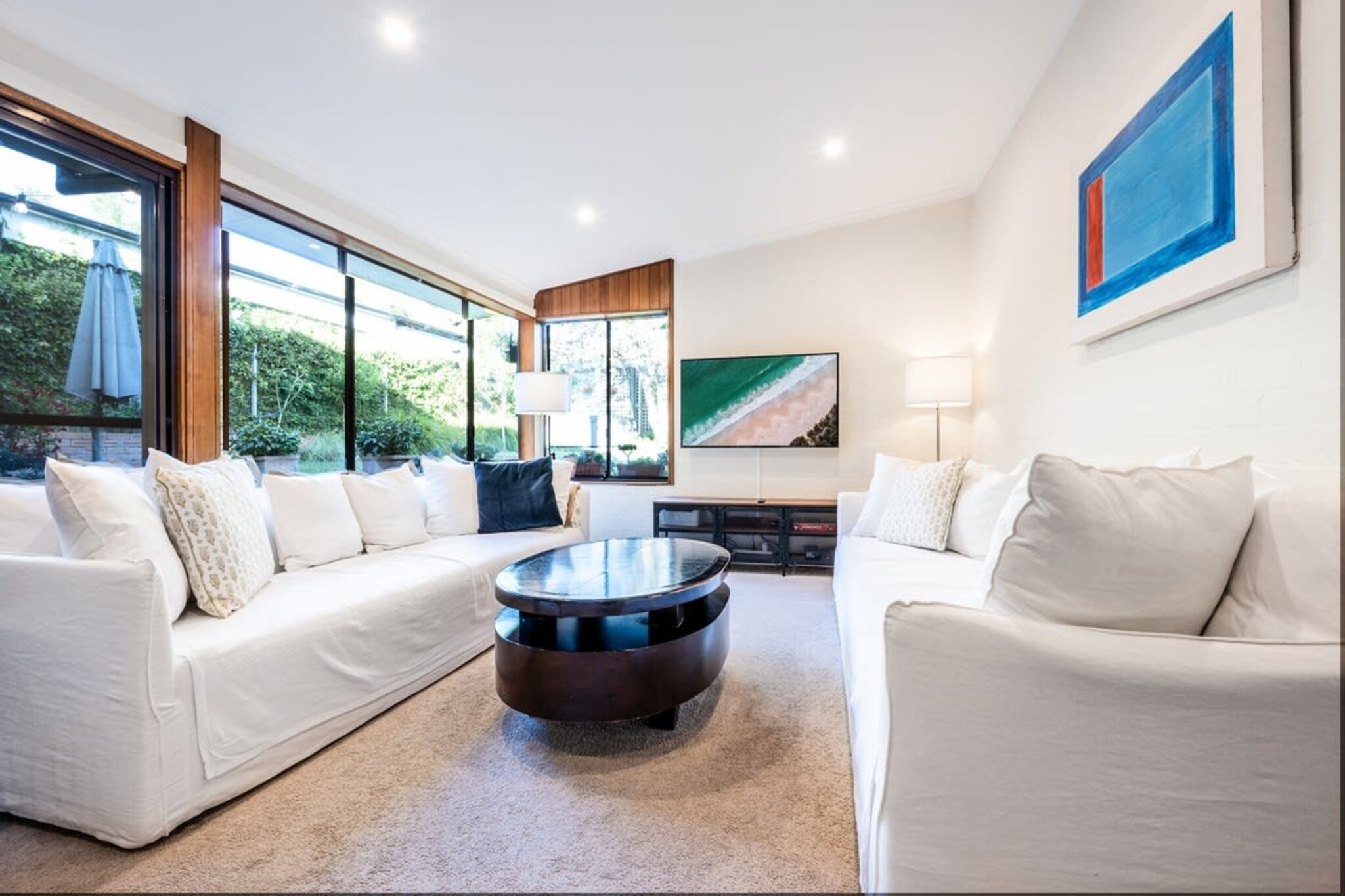 Relish in Sydney’s affluent eastern suburbs in this delightful 4-bed house a short drive from Bronte Beach. Featuring sleek interiors this elevated classical home features generous bedrooms, a garden and alfresco dining spaces to indulge in. Situated metres from Queens Park and Bronte Road, the home offers proximity to the Centennial Parklands, Bondi Junction shops and iconic Bronte Beach. Perfect for those seeking a peaceful base to explore the city, this is the spot for you.
The space
Classically designed, this elevated house features homely decor that’s accentuated by an abundance of natural light and warm wooden tones. Offering an open-plan living area, study areas, kitchen, modern appliances, sleek bathrooms, generous bedrooms with either dressing rooms or backyard access, a master WIR and ensuite, along with a generous garden with alfresco dining available. Relish in this refined property's expertly curated atmosphere for yourself.
 
General
- Chic 4-bedroom, 2-bathroom house.
- Contemporary interiors with chic decor and furnishings.
- Wifi available.
- Close to public transport.
- Study areas available for use.
- Generous backyard with an alfresco dining area with outdoor seating.
- Great location moments from local shops, parks and the iconic beachside.
 
Bedroom
- Bedroom 1: 1x Queen Bed with a study nook, WIR and ensuite.
- Bedroom 2: 1x Double Bed with a dressing room.
- Bedroom 3: 1x Double Bed with a dressing room.
- Bedroom 4: 1x Double Bed with courtyard access.
- Air conditioning and heating available.
 
Living Room
- Plush couches and a coffee table.
- TV with free-to-air and streaming options (use your own account)
- 8-seater dining table available.
 
Kitchen
- Fully equipped with cookware, utensils and cutlery.
- Toaster, kettle, coffee machine and microwave.
- Oven and gas stovetop available.
- Dishwasher available.
 
Bathroom & Laundry
- Sleek bathrooms.
- Laundry unit available with a washer and dryer.
- Travel essentials, towels and hairdryer provided.
 
Points of Interest
Queen Park - 1 minute (80m) walk away.
Bronte Rd Shopping and Dining Strip - 2 minutes (200m) walk away.
Bronte Park, Baths and Beach - 5 minutes (1.8km) drive away.
Local area description
Queens Park is a picturesque residential neighbourhood situated in Sydney’s affluent Eastern Suburbs. Known for its expensive namesake park, the suburb neighbours the expansive Centennial Parklands encompassing ponds, ovals, gardens and a homestead to enjoy. Bordering the bustling Bronte St and Bondi Junction the suburb offers proximity to energetic shopping centres, restaurants, bars and cafes ripe for exploration. Only a short drive from the popular Bronte Beach, Bondi Beach and CBD the pristine Queens Park is the perfect residential hideaway.
House rules
You are staying in a friendly and peaceful neighbourhood and we kindly ask you to respect the community and your surrounding neighbours. The following strict House Rules apply:
 
- No loud noise between 10 pm and 8 am
- No parties or antisocial behaviour
- No additional people are to access the property without our prior approval
- No pets are allowed in the property without approval
- No smoking is allowed at any times
- If you break something, please let us know
 
- To help protect all floor coverings do not wear any shoes inside the property
 
Please be aware that excessive noise such as amplified music, vocals or screaming or anti-social behaviour in the property or common areas can cause neighbours to complain to us, the Building Manager, Council Rangers or Police.
 
IMPORTANT: Any breach of the House Rules may lead to a $500 fine plus compensation for any cost/damage created and immediate eviction of the property.
 
Finally, when checking out, we kindly ask you for the following:
 
- Please leave all beds unmade
- Please clean up your dishes and put them away
- In case you have rearranged furniture, please put it back to the original location
- Please take out the rubbish and remember to use the right bins
- Please ensure all appliances, A/C and lights are off and doors and windows are closed.
Interaction with guests
Welcome to MadeComfy! Our local team curates stays in exceptional Australian & New Zealand properties, ensuring style, comfort, and prime locations for discerning guests. We prioritise your needs to provide a memorable home-away-from-home experience. Explore our digital guidebooks for local recommendations, and don't hesitate to contact us throughout your stay. We're here to ensure your comfort – enjoy your stay with MadeComfy.
Notes
- For your comfort, this property is prepared with professional-grade hotel-style linen, including a three-sheet setup, ensuring a fresh and hygienic sleep experience.
- There is no on-site parking and all street parking is limited to 2P. Though nearby streets have unlimited parking available.
 
Extra Services:
- Early check-in: Our standard check-in is at 3 pm. To guarantee early access to the property we suggest booking the night before if available. Otherwise, early check-in is subject to availability from the night before at an additional cost.
- Late check-out: Our standard check-out is at 10 am. To guarantee a later check-out of the property we suggest booking an additional night if available. Otherwise, a late check-out is subject to availability from the night before to an additional cost.
- Baggage: For security reasons, we are unable to receive or to keep unattended baggage before check-in or after check-out
- We provide a small welcome amenity pack to get your stay started
- No pets allowed.
- This booking is protected with coverage for lost baggage and emergency medical expenses, provided by Travel Support with claim upto 500 AUD (T&C Applies). For more details reach out to Guest Support team post booking.
Access description
- To access the property, from the street use the steps to the front door.
- You’ll have access to the entire property when you stay here, so it will feel like your own home.
- The keys are left in a lockbox onsite.
- There are stairs outside and inside the property.
Getting around
Public transport
The property is a short walk from multiple bus stops operating trips to Bondi Junction, Coogee Beach, North Bondi, Bronte, Domestic Airport, Clovelly and Waverly.
 
Ride sharing
There are plenty of taxi and ride-sharing options readily available throughout Queens Park.
 
Points of Interest
Queen Park - 1 minute (80m) walk away.
Bronte Rd Shopping and Dining Strip - 2 minutes (200m) walk away.
Bronte Park, Baths and Beach - 5 minutes (1.8km) drive away.
 
Getting there
The property is approximately a 25-minute drive from Sydney Airport.