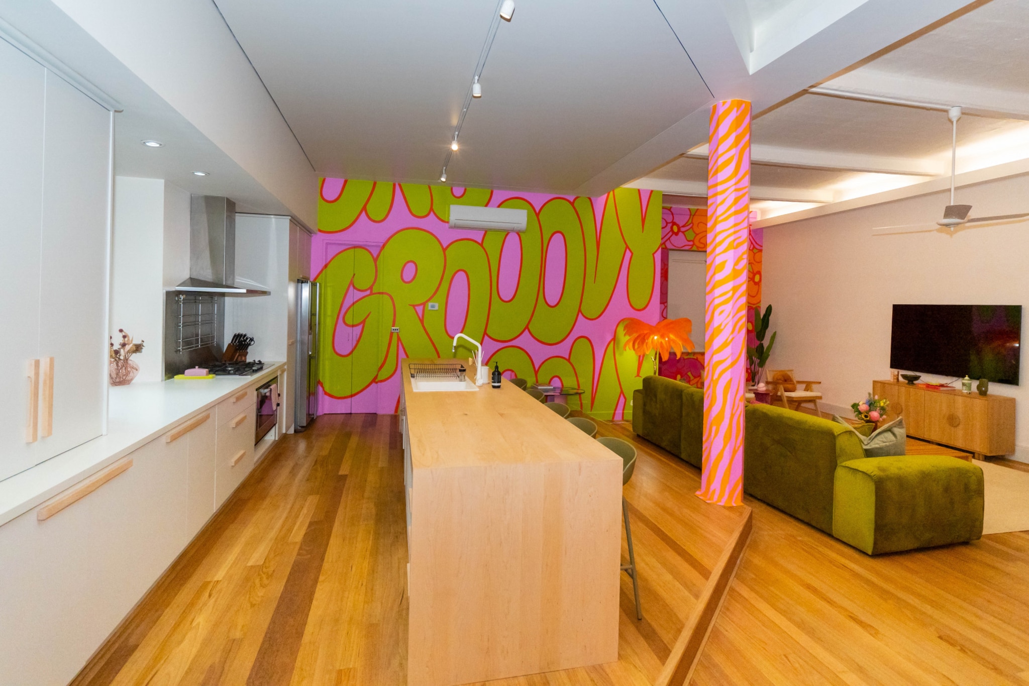 Property description
Appreciate the iconic Melbourne in this unbeatable 3-bed apartment located in the city’s centre. Featuring funky 70s-inspired interiors, this modern property offers charmingly comfortable bedrooms, as well as laundry facilities, a dishwasher and on-site parking. Situated in the heart of the city, the apartment boasts close proximity to cafes, shops, bars, attractions and more. Perfect for those wanting to explore Melbourne from a fun unique apartment, this place is yours!
The space
Beautifully designed, this modest apartment offers a chic and fun open living plan with a fully stocked kitchen, modern appliances, clean bathrooms, comfortable bedrooms, and underground parking - this property is an idyllic city stay. A large apartment with lots of colour and greenery, you’ll have plenty of photo opportunities.
 
General
- Entire 3 bedroom apartment with 2 bathrooms
- Spacious and bright 70s inspired interiors
- Air conditioning and heating available
- Wi-Fi provided
- Laundry unit with washer and dryer
- On-site underground parking
 
Bedroom & Bathroom
- Bedroom 1: 1x King bed
- Bedroom 2: 1 x Queen bed
- Bedroom 3: 2 x Single beds with pull out trundles underneath
- 2 x Spacious bathrooms with toiletries and towels provided
 
Kitchen
- Fully equipped with utensils and cutlery
- Toaster, coffee machine, dishwasher and microwave available
- Oven and gas stovetop
 
Living / Dining Room
- Comfortable lounge and dining setting for 8
- TV available with free-to-air options
 
Points of Interest
- Melbourne CBD is at your doorstep
- Queen Victoria Market is a 25 min walk
- Emporium Melbourne is a 12 min walk
- Crown Casino is an 18 min walk
Local area description
Melbourne CBD is the bustling heart of this famous artistic Australian metropolis. Being home to some of Melbourne's most iconic sites such as the Flinders Street Station and Federation Square, the city is always bursting at the seams with things to do. Home to a thriving cafe and restaurant culture, dive right into the culinary mastery of the local business. Go shopping in the myriad of famous, fashionable or even boutique stores. Only a short tram ride away from all the hip inner-city suburbs or the picturesque Port Phillip bayside, Melbourne CBD is the destination for a trip to this sprawling city.
House rules
You are staying in a friendly and peaceful neighbourhood and we kindly ask you to respect the community and your surrounding neighbours. The following strict House Rules apply:
 
- No loud noise between 10 pm and 8 am
- No disruptive parties regardless of size or any antisocial behaviour
- No additional people are to access the property without our prior approval
- No pets are allowed on the property without approval
- No smoking is allowed at any times
- If you break something, please let us know
- To help protect all floor coverings do not wear any shoes inside the property
 
Please be aware that excessive noise such as amplified music, vocals or screaming or anti-social behaviour in the property or common areas can cause neighbours to complain to us, the Building Manager, Council Rangers or Police.
 
IMPORTANT: Any breach of the House Rules may lead to a $500 fine plus compensation for any cost/damage created and immediate eviction of the property.
 
Finally, when checking out, we kindly ask you for the following:
 
- Please leave all beds unmade
- Please clean up your dishes and put them away
- In case you have rearranged furniture, please put it back to the original location
- Please take out the rubbish and remember to use the right bins
- Please ensure all appliances, A/C and lights are off and doors and windows are closed
Interaction with guests
Welcome to MadeComfy! Our local team curates stays in exceptional Australian & New Zealand properties, ensuring style, comfort, and prime locations for discerning guests. We prioritise your needs to provide a memorable home-away-from-home experience. Explore our digital guidebooks for local recommendations, and don't hesitate to contact us throughout your stay. We're here to ensure your comfort – enjoy your stay with MadeComfy.
Notes
For your comfort, this property is prepared with professional-grade hotel-style linen, including a three-sheet setup, ensuring a fresh and hygienic sleep experience.
 
Please keep noise level to a minimum between 10pm and 8am for neighbours. Excessive noise could lead to an on-the-spot AUD500 fine and/or eviction from the property.
 
Extra Services:
- Early check-in: Our standard check-in is at 3 pm. To guarantee early access to the property we suggest booking the night before if available. Otherwise, early check-in is subject to availability from the night before at an additional cost.
- Late check-out: Our standard check-out is at 10 am. To guarantee a later check-out of the property we suggest booking an additional night if available. Otherwise, a late check-out is subject to availability from the night before to an additional cost.
- Baggage: For security reasons, we are unable to receive or to keep unattended baggage before check-in or after check-out
- We provide a small welcome amenity pack to get your stay started
- Cleaning services are available during your stay for an additional cost. Inform us and we'll organise it for you
- Pets allowed upon approved requests, additional fees apply
- Parking suitable for small-sized cars only due to height restrictions
- This booking is protected with coverage for lost baggage and emergency medical expenses, provided by Travel Support with claim upto 500 AUD (T&C Applies). For more details reach out to Guest Support team post booking.
Access description
You’ll have access to the entire property when you stay here, so it will feel like your own home.
Getting around
Public transport
Public transport is a breeze with the lightrail at your doorstep. Check out the TripGo app for transport timetables.
 
 
Ride sharing
We highly recommend using ride-sharing services: For first time users, download the Uber app for more information.
 
Points of Interest
- Melbourne CBD is at your doorstep
- Queen Victoria Market is a 25 min walk
- Emporium Melbourne is a 12 min walk
- Crown Casino is an 18 min walk
 
Getting there
The property is approximately a 35 min drive from Tullamarine Airport and 50 min drive from Avalon Airport