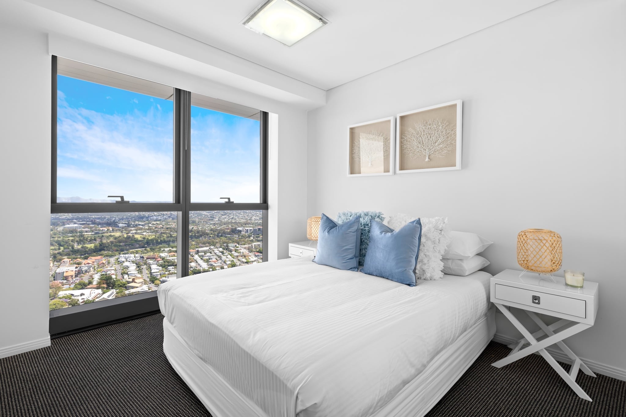 Enrich your Brisbane stay in this sleek 2-bed apartment with incredible views of the Brisbane River. Featuring chic interiors with on-site parking sauna and gym facilities, this central property is an idyllic city base. Centrally located near local cafes, restaurants and shops, enjoy proximity to the popular Howard Smith Wharves, Fortitude Music Hall and the city centre. Perfect for those wanting an elegant holiday stay, this apartment is the one for you.
The space
Generously designed, this stylish property offers sleek interiors combined with an elegant abundance of natural light. Featuring an open-plan living area, a sleek kitchen with countertop seating, modern appliances, elegant bathrooms, comfy bedrooms and stunning views. This property is a truly idyllic spot in an undeniably prime location.
 
General
- Modern 2-bedroom, 2-bathroom apartment
- Air conditioner and heater available
- Contemporary interiors with elegant decor
- On-site parking is available for 1 car
- On-site gym and sauna facilities readily available
- Wi-Fi is available
- Self check-in
 
Bedroom & bathroom
- Bedroom 1: 1x King Bed, blackout blinds with a WIR and ensuite
- Bedroom 2: 1x Queen Bed and blackout blinds
- Sleek modern bathrooms
- Laundry unit with washer and dryer available
- Travel essentials, towels and hairdryer provided
 
Kitchen
- Fully stocked with cookware, utensils and cutlery
- Kettle, toaster, coffee machine and microwave available
- Oven and gas stovetop available
- Dishwasher available
- 4-seater countertop area
 
Living Room
- Couches, armchairs and coffee table
- TV with free-to-air and streaming options available
- 4-seater dining table
- Black-out blinds
 
Points of Interest
Queen Street Mall - 14 min walk
Howard Smith Wharves - 4 minutes (250m) walk away
Spring Hill Marketplace Shopping Centre - 4 minutes (350m) walk away
Fortitude Music Hall - 9 minutes (650m) walk away
Local area description
Brisbane City is the energetic heart of this iconic metropolis. Bustling with activity there's no limit to the number of things to see. Popular with shoppers peruse the busy Queen St Mall selection from luxury brands to boutique stores. For those looking to indulge themselves, you’ll never be far from a vibrant cafe, bar or restaurant that’ll meet all your culinary needs. Situated along the banks of the Brisbane river, experience the stunning waterfront walks or pop into the lush Botanic Gardens, perfect for picnics or experiencing the weekly markets. Bursting with adventure Brisbane City is the destination for your next trip.
House rules
You are staying in a friendly and peaceful neighbourhood and we kindly ask you to respect the community and your surrounding neighbours. The following strict House Rules apply:
- No loud noise between 10 pm and 8 am
- No parties or antisocial behaviour
- No additional people are to access the property without our prior approval
- No pets are allowed in the property without approval
- No smoking is allowed at any times
- If you break something, please let us know
 
- To help protect all floor coverings do not wear any shoes inside the property
 
Please be aware that excessive noise such as amplified music, vocals or screaming or anti-social behaviour in the property or common areas can cause neighbours to complain to us, the Building Manager, Council Rangers or Police.
 
IMPORTANT: Any breach of the House Rules may lead to a $500 fine plus compensation for any cost/damage created and immediate eviction of the property.
 
Finally, when checking out, we kindly ask you for the following:
- Please leave all beds unmade
- Please clean up your dishes and put them away
- In case you have rearranged furniture, please put it back to the original location
- Please take out the rubbish and remember to use the right bins
- Please ensure all appliances, A/C and lights are off and doors and windows are closed
Interaction with guests
Welcome to MadeComfy! Our local team curates stays in exceptional Australian & New Zealand properties, ensuring style, comfort, and prime locations for discerning guests. We prioritise your needs to provide a memorable home-away-from-home experience. Explore our digital guidebooks for local recommendations, and don't hesitate to contact us throughout your stay. We're here to ensure your comfort – enjoy your stay with MadeComfy.
Notes
- For your comfort, this property is prepared with professional-grade hotel-style linen, including a three-sheet setup, ensuring a fresh and hygienic sleep experience.
- Air conditioning is in the living and both bedrooms.
- There are no stairs inside the property.
- Hotel service is not applicable
- Blackout blinds are in the bedrooms and living rooms.
- The property is on level 60 - please note for guests with height issues.
- To access the on-site parking take the Adelaide Street garage entrance and drive to level 7.
- Pool, Sauna and Gym – level 5
- Please keep the noise level to a minimum between 10 pm and 8 am for neighbours. Excessive noise could lead to an on-the-spot AUD500 fine and/or eviction from the property.
 
 
Extra Services:
- Early check-in: Our standard check-in is at 3 pm. To guarantee early access to the property we suggest booking the night before if available. Otherwise, early check-in is subject to availability from the night before at an additional cost.
- Late check-out: Our standard check-out is at 10 am. To guarantee a later check-out of the property we suggest booking an additional night if available. Otherwise, a late check-out is subject to availability from the night before to an additional cost.
- Baggage: For security reasons, we are unable to receive or to keep unattended baggage before check-in or after check-out
- We provide a small welcome amenity pack to get your stay started
- This booking is protected with coverage for lost baggage and emergency medical expenses, provided by Travel Support with claim upto 500 AUD (T&C Applies). For more details reach out to Guest Support team post booking.
Access description
- Key collection is offsite, 140 meters from the property and not available 24/7. Further details will be provided 3 days before check-in if your booking is successfully reserved.
Getting around
Public transport
The property is located near numerous bus stops operating trips to Woolloongabba Station, Toombul Interchange, Valley, Teneriffe Ferry, Chermside Interchange, New Farm, Stafford City, City, West End Ferry, Bardon, Cultural Centre, Ashgrove, Wynnum Plaza. Additionally, the property is right between both Brisbane and Fortitude Valley Train Stations operating routes along all major city lines.
 
Ride sharing
There is plenty of taxi and ride-sharing options readily available throughout Brisbane.
 
Points of Interest
Queen Street Mall - 14 min walk.
Howard Smith Wharves - 4 minutes (250m) walk away.
Spring Hill Marketplace Shopping Centre - 4 minutes (350m) walk away.
Fortitude Music Hall - 9 minutes (650m) walk away.
 
Getting there
The property is roughly an 20-minute drive from Brisbane Airport.