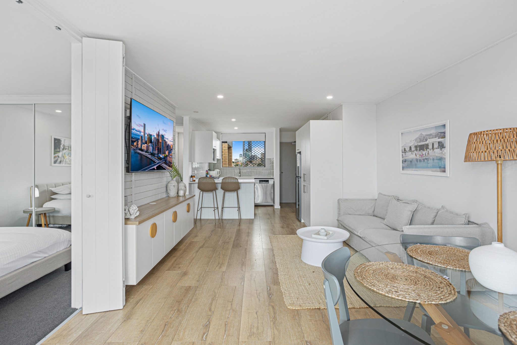 Explore one of the most vibrant inner suburbs of Brisbane in this spacious 1-bed in the heart of Teneriffe. With charming interiors, this property offers a peaceful refuge and a private balcony with outdoor seating. It is situated 2.5km from the CBD and moments away from Brisbane’s premier shopping and dining precinct, James Street. Fortitude Valley, with several bustling bars, pubs and clubs is within walking distance making this property a fantastic base to explore what Brisbane has to offer.
The space
Generously designed this cosy 1-bed unit offers sleek homely interiors coupled with an abundance of natural light to create a calmingly modern vibe. With its open living plan design, its sleek kitchen, modern appliances, countertop seating, a polished bathroom, a comfy bedroom area and a private balcony with outdoor seating. This property is the perfect Brisbane spot for any curious traveller.
 
General
- Modern 1-bedroom, 1-bathroom apartment
- On-site parking (1 car)
- Wi-Fi is provided
- Air conditioning and heating
- Sleek interiors with chic homely decor
- Private balcony with outdoor seating
- Self check-in
 
Bedroom & bathroom
- Bedroom 1: 1x King Bed
- Sleek modern bathroom with a bathtub
- Laundry room available (washer only)
- Travel essentials, towels and hairdryer provided
 
Kitchen
- Fully equipped with cookware, utensils and cutlery
- Kettle, toaster, coffee machine and microwave
- Oven and gas stovetop
- Dishwasher available
- 2-seater countertop seating
 
Living Room
- Generously plush couches and ottomans
- TV with free-to-air and streaming options
- 4-seater outdoor dining table
 
Points of Interest
Commercial St Dining Strip - 4 minutes (250m) walk away
James St Shopping and Dining Strip – 6 minutes (500m) walk away
GAswork Plaza Shopping Centre - 8 minutes (600m) walk away
Local area description
Teneriffe is a breezy Brisbane suburb known for its riverside location and leafy residential area. Set along the northern shores of the Brisbane River enjoy the suburbs' riverwalk and park featuring calming pockets of nature. Home to the vibrant cafe, restaurant and bar scenes Teneriffe offers quaint alternatives to the bustling city food scene. Neighbouring the bustling Fortitude Valley, the suburb offers a peaceful refuge while still being close to the energetic Valley's live music venues, pubs and bars. With all its pros Teneriffe is undoubtedly a pristine Brisbane suburb ripe with opportunity.
House rules
You are staying in a friendly and peaceful neighbourhood and we kindly ask you to respect the community and your surrounding neighbours. The following strict House Rules apply:
- No loud noise between 10 pm and 8 am
- No parties or antisocial behaviour
- No additional people are to access the property without our prior approval
- No pets are allowed in the property without approval
- No smoking is allowed at any times
- If you break something, please let us know
 
- To help protect all floor coverings do not wear any shoes inside the property
 
Please be aware that excessive noise such as amplified music, vocals or screaming or anti-social behaviour in the property or common areas can cause neighbours to complain to us, the Building Manager, Council Rangers or Police.
 
IMPORTANT: Any breach of the House Rules may lead to a $500 fine plus compensation for any cost/damage created and immediate eviction of the property.
 
Finally, when checking out, we kindly ask you for the following:
- Please leave all beds unmade
- Please clean up your dishes and put them away
- In case you have rearranged furniture, please put it back to the original location
- Please take out the rubbish and remember to use the right bins
- Please ensure all appliances, A/C and lights are off and doors and windows are closed
Interaction with guests
Welcome to MadeComfy! Our local team curates stays in exceptional Australian & New Zealand properties, ensuring style, comfort, and prime locations for discerning guests. We prioritise your needs to provide a memorable home-away-from-home experience. Explore our digital guidebooks for local recommendations, and don't hesitate to contact us throughout your stay. We're here to ensure your comfort – enjoy your stay with MadeComfy.
Notes
- For your comfort, this property is prepared with professional-grade hotel-style linen, including a three-sheet setup, ensuring a fresh and hygienic sleep experience.
- The building has no elevator (stair access only)
- Air conditioning in the living room only.
- To access the one-site car spot use the garage entrance on the right-hand side of the main entrance.
- Please keep the noise level to a minimum between 10pm and 8am for neighbours. Excessive noise could lead to an on-the-spot AUD500 fine and/or eviction from the property.
 
Extra Services:
- Early check-in: Our standard check-in is at 3 pm. To guarantee early access to the property we suggest booking the night before if available. Otherwise, early check-in is subject to availability from the night before at an additional cost.
- Late check-out: Our standard check-out is at 10 am. To guarantee a later check-out of the property we suggest booking an additional night if available. Otherwise, a late check-out is subject to availability from the night before to an additional cost.
- Baggage: For security reasons, we are unable to receive or to keep unattended baggage before check-in or after check-out
- We provide a small welcome amenity pack to get your stay started
- Cleaning services are available during your stay for an additional cost. Inform us and we'll organise it for you
- This booking is protected with coverage for lost baggage and emergency medical expenses, provided by Travel Support with claim upto 500 AUD (T&C Applies). For more details reach out to Guest Support team post booking.
Access description
You’ll have access to the entire property when you stay here, so it will feel like your own home.
- The keys will be left in a lockbox onsite. We will send you the access code 3 days prior to your arrival through the booking portal.
Getting around
Public transport
Property is located by bus stops operating trips to Teneriffe Ferry and Toowong Village.
 
Ride sharing
There are plenty of taxi and ride-sharing options readily available throughout Brisbane.
 
Points of Interest
Commercial St Dining Strip - 4 minutes (250m) walk away
James St Shopping and Dining Strip – 6 minutes (500m) walk away
GAswork Plaza Shopping Centre - 8 minutes (600m) walk away
 
Getting there
Property is approximately a 15-minute drive from Brisbane Airport.