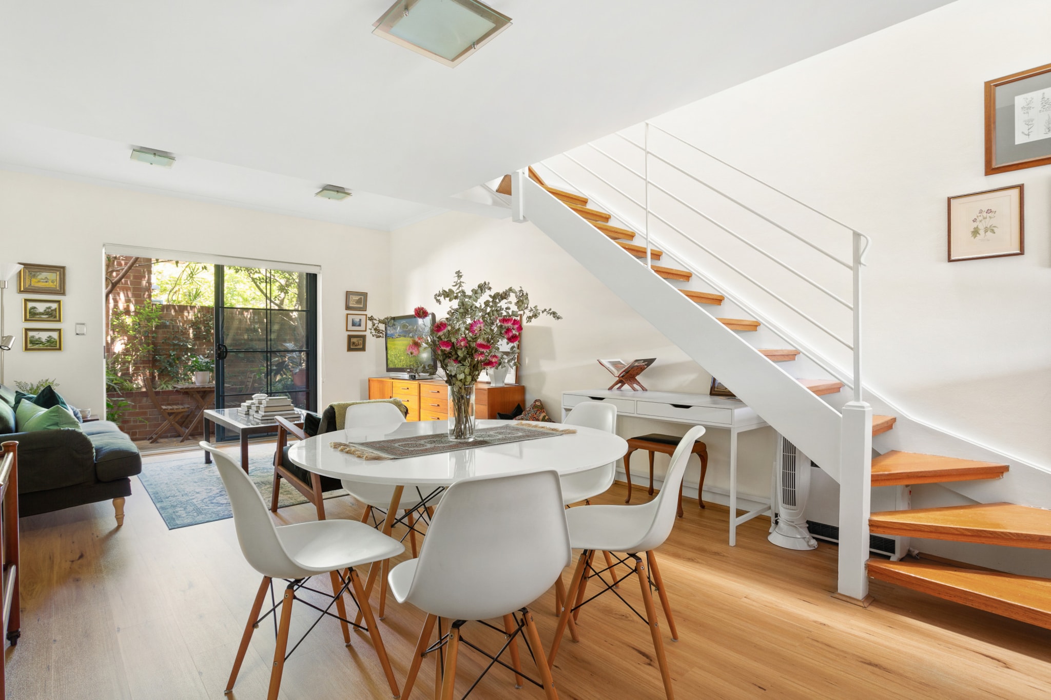 Spacious 2-Bed Townhouse with a Lush Courtyard