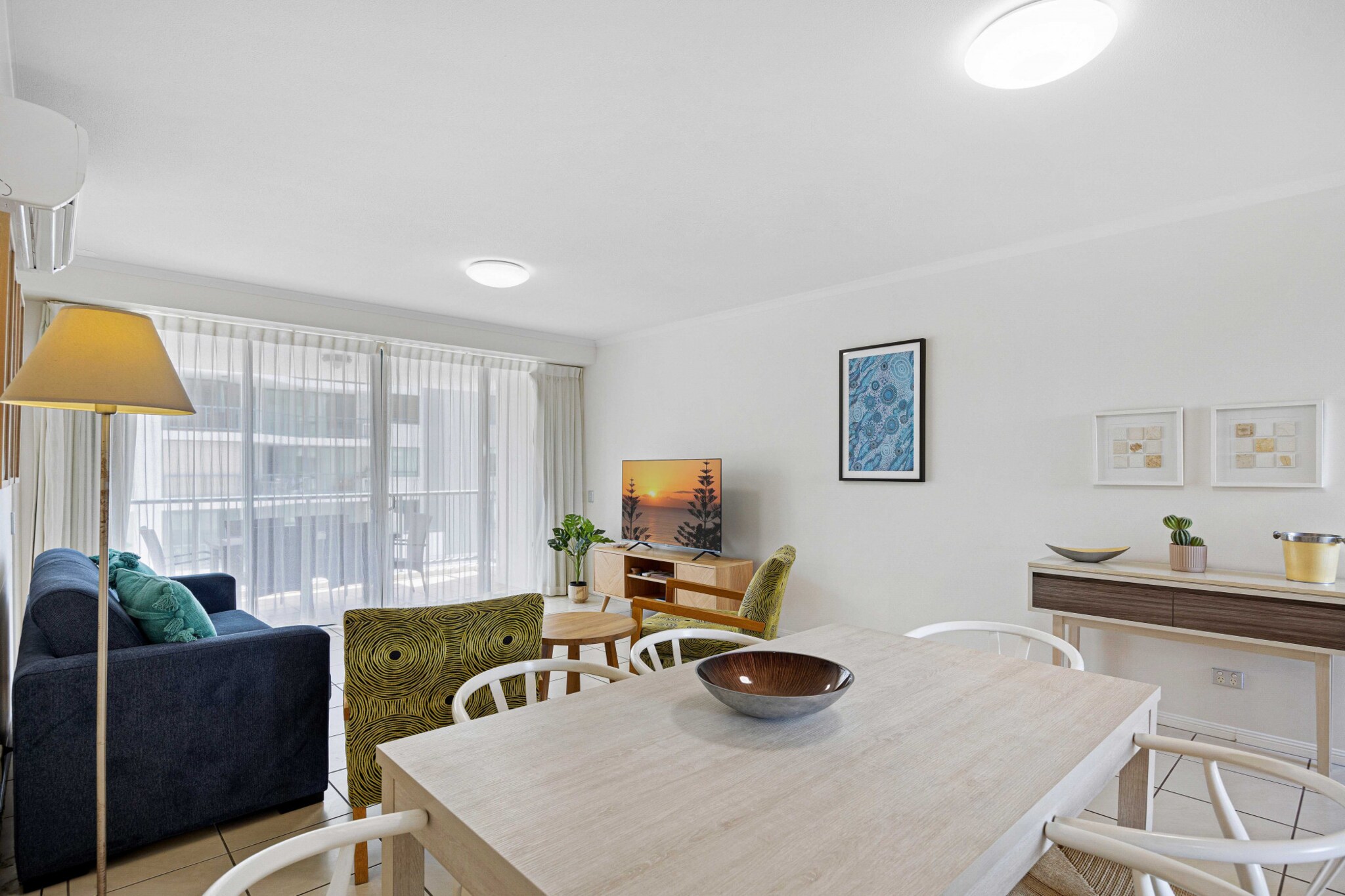 Located just steps from one of the Sunshine Coast’s most iconic surf beaches, this stunning 2-bed, 2-bath apt offers the ultimate beachside escape. Nestled in a luxurious resort-style complex, enjoy access to an on-site gym, sparkling pools, & BBQ areas. The spacious balcony, complete with ocean views, is perfect for outdoor dining or sipping your morning coffee while listening to the waves. With parks, shops, & top-rated restaurants just a short walk away, every convenience is at your doorstep.
The space
This sun-filled, airy apartment showcases modern coastal elegance, with high-end finishes and an open-plan layout that maximizes space and light. The well-appointed kitchen features sleek stone benchtops, perfect for those who love to cook. Both bedrooms are designed for relaxation, and the two luxury bathrooms add a touch of spa-like indulgence. Unwind on the balcony with refreshing ocean breezes, just steps from the sandy shores—your perfect getaway awaits!
 
General
- Spacious 2-bedroom, 2-bathroom apartment
- Wi-Fi is available
- On-site parking
- Reverse cycle air-conditioning and fans
- Onsite gym, BBQ area and two pools
- Stylish interiors with contemporary decor and furnishings
- Generous balcony with views and outdoor dining
- Easy access to public transport
- Fantastic location close to restaurants, cafes and surf beach
- Self check-in
 
Bedroom
- Bedroom 1: 1x King Bed
- Bedroom 2: 2x Single Beds
- Reverse cycle air-conditioning
 
Living Room
- Comfortable couch which converts to the queen-sized sofa bed
- TV with free-to-air and streaming options
- Reverse cycle air-conditioning
- 6-seater dining table
 
Kitchen
- Fully equipped with cookware, utensils and cutlery
- Fridge freezer
- Toaster, coffee machine and microwave.
- Electric oven and stovetop.
- Dishwasher.
 
Bathroom & Laundry
- Newly renovated bathrooms
- Laundry unit with a washer and dryer
- Travel essentials, towels and hairdryers
 
Points of Interest
- Alexandra Headland Beach - 3 minutes (160m) walk away
- Nelson Park - 4 minutes (300m) walk away
- Sunshine Plaza - 8 minutes (2.9km) drive away
Local area description
Alexandra Headland is a bustling seaside town located in the heart of the famous Sunshine Coast region. Situated along Alexandra Beach facing out towards the pacific ocean, the suburb is a popular holiday destination. Featuring numerous bustling dining venues along its main promenade the suburb also offers numerous parks and a conference centre. Located near the Sunshine Plaza, the town is a commercial hub with numerous shops, cafes and restaurants readily available throughout. With gorgeous beachfront and numerous dining venues, Alexandra Headland is a prime location for your next coastal getaway.
House rules
You are staying in a friendly and peaceful neighbourhood and we kindly ask you to respect the community and your surrounding neighbours. The following strict House Rules apply:
- No loud noise between 10 pm and 8 am
- No parties or antisocial behaviour
- No additional people are to access the property without our prior approval
- No pets are allowed in the property
- No smoking is allowed at any times
- If you break something, please let us know
 
- To help protect all floor coverings do not wear any shoes inside the property
 
Please be aware that excessive noise such as amplified music, vocals or screaming or anti-social behaviour in the property or common areas can cause neighbours to complain to us, the Building Manager, Council Rangers or Police.
 
IMPORTANT: Any breach of the House Rules may lead to a $500 fine plus compensation for any cost/damage created and immediate eviction of the property.
 
Finally, when checking out, we kindly ask you for the following:
- Please leave all beds unmade
- Please clean up your dishes and put them away
- In case you have rearranged furniture, please put it back to the original location
- Please take out the rubbish and remember to use the right bins
- Please ensure all appliances, A/C and lights are off and doors and windows are closed.
Interaction with guests
Welcome to MadeComfy! Our local team curates stays in exceptional Australian & New Zealand properties, ensuring style, comfort, and prime locations for discerning guests. We prioritise your needs to provide a memorable home-away-from-home experience. Explore our digital guidebooks for local recommendations, and don't hesitate to contact us throughout your stay. We're here to ensure your comfort – enjoy your stay with MadeComfy.
Notes
- For your comfort, this property is prepared with professional-grade hotel-style linen, including a three-sheet setup, ensuring a fresh and hygienic sleep experience.
- To access the on-site parking, drive between buildings and down the driveway on left.
- There are no stairs inside and outside the property.
- Cooking oil is not provided
 
Extra Services:
- Early check-in: Our standard check-in is at 3 pm. To guarantee early access to the property we suggest booking the night before if available. Otherwise, early check-in is subject to availability from the night before at an additional cost.
- Late check-out: Our standard check-out is at 10 am. To guarantee a later check-out of the property we suggest booking an additional night if available. Otherwise, a late check-out is subject to availability from the night before to an additional cost.
- Baggage: For security reasons, we are unable to receive or to keep unattended baggage before check-in or after check-out
- We provide a small welcome amenity pack to get your stay started
- No pets allowed.
- This booking is protected with coverage for lost baggage and emergency medical expenses, provided by Travel Support with claim upto 500 AUD (T&C Applies). For more details reach out to Guest Support team post booking.
Access description
The keys will be left in a lockbox. We will send you the access code 3 days prior to your arrival through the booking portal.
You’ll have access to the entire property when you stay here, so it will feel like your own home.
Getting around
Public transport
The property is near bus stops on Alexandra Parade and Okinja Rd operating trips to Caloundra station, Maroochydore station, Kawana Forest, Palmview, Lands Shoppingworld, Cairns and Brisbane.
 
Ride sharing
There is plenty of taxi and ride-sharing options readily available throughout the Sunshine Coast. Though we recommend booking in advance due to low availability.
 
Points of Interest
Alexandra Headland Beach - 3 minutes (160m) walk away.
Nelson Park - 4 minutes (300m) walk away.
Sunshine Plaza - 8 minutes (2.9km) drive away.
 
Nearby Attractions
Underwater world, Australia Zoo, Chambers Island, Nights on Ocean (markets), Cotton Tree, Cotton Tree markets, Adventure Ropes Course, Timezone Sunshine Plaza
 
Getting there
The property is roughly a 15-minute drive from Sunshine Coast Airport and a 1-hour 40-minute drive from Brisbane.