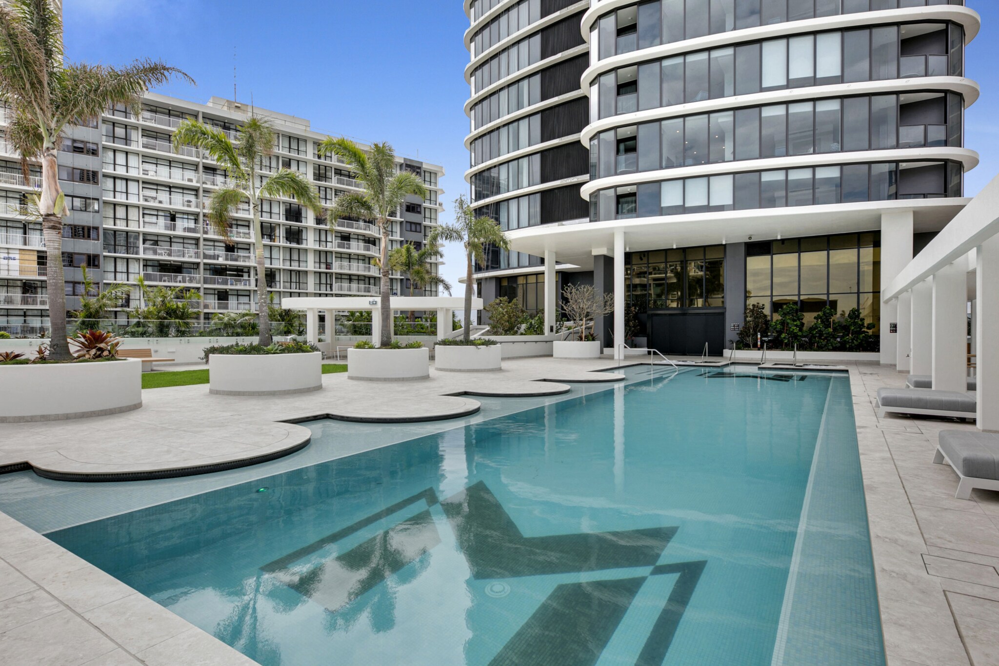Indulge in the vibrant Surfer's Paradise in this luxurious 3-bed apartment with phenomenal views. Situated across from the iconic beach and minutes from the popular Cavill Ave shops, relish in the abundant dining, entertainment and nightlife venues all only moments from the property. Featuring premium interiors this property’s panoramic views and access to on-site amenities make it the perfect refuge for a beachside holiday, perfect for those who want to live in luxury.
The space
Take in the uninterrupted views across the Pacific Ocean as you relax and unwind poolside on Level 33. Meticulously designed, this impeccable apartment offers sleek contemporary interiors with an abundance of natural light to create a spacious and welcoming feel. Featuring an open-plan living area, premium appliances, a sleek kitchen, polished bathrooms, gorgeous bedrooms and uninterrupted panoramic views of the ocean, skyline and hinterlands. Experience for yourself this property’s pristine atmosphere and gorgeous interiors equipped with everything you’d need for an unforgettable stay.
 
General
- Premium 3-bedroom, 2-bathroom apartment
- Wi-Fi is available
- On-site parking available
- Close to public transport
- Blackout blinds available
- A/C and heating available
- On-site gym and pool facilities available
- Luxurious interiors with bright decor and modern furnishings
- Incredibly expansive ocean, skyline and hinterland views available
- Fantastic location moments from Cavill Avenue Shops and the iconic beach
- Self check-in
 
Bedroom
- Bedroom 1: 1x King Bed
- Bedroom 2: 2x Single Beds
- Bedroom 3: Bunk Bed (1x Double Bed and 1x Single Bed)
- Additional sofa bed available
- Blackout blinds available
- A/C and heating available
 
Living Room &
- Plush couch and a coffee table are available
- TV with streaming options available
- A/C and heating available
- Blackout blinds available
- 6-seater dining table
 
Kitchen
- Fully stocked with appliances
- Kettle, microwave and coffee maker available
- Oven and gas stovetop available
- 2-seater counter area
 
Bathroom & Laundry
- Sleek bathroom available
- Travel essentials, towels and hairdryer provided
- Laundry room available with washer and dryer
 
Points of Interest
Surfers Paradise Beach - 1 minute (50m) walk away
Chevron Renaissance Shopping Centre – 7 minutes (550m) walk away
Cavill Avenue Shopping Strip and Markets - 9 minutes (750m) walk away
"Soul Broadwalk" Shopping & Dinning - 7 minutes (600m) walk away
Local area description
Surfers Paradise is one of Australia’s most famous tourist attractions, experience this unique cosmopolitan life only steps away from the iconic Surfers Paradise beach. Known for its bustling atmosphere, there’s no short of adventure to be experienced at this famous beachside getaway. With one of the busiest shopping and entertainment districts found in Australia on the nearby Cavill Avenue, Surfers is a hotspot for everything nightlife related. From cafes and restaurants to pubs and clubs there’s something for everyone. Known for its year-round warm weather and friendly locals, Surfers Paradise is the ideal holiday destination.
House rules
You are staying in a friendly and peaceful neighbourhood and we kindly ask you to respect the community and your surrounding neighbours. The following strict House Rules apply:
- No loud noise between 10 pm and 8 am
- No parties or antisocial behaviour
- No additional people are to access the property without our prior approval
- No pets are allowed in the property without approval
- No smoking is allowed at any times
- If you break something, please let us know
- To help protect all floor coverings do not wear any shoes inside the property
 
Please be aware that excessive noise such as amplified music, vocals or screaming or anti-social behaviour in the property or common areas can cause neighbours to complain to us, the Building Manager, Council Rangers or Police.
 
IMPORTANT: Any breach of the House Rules may lead to a $500 fine plus compensation for any cost/damage created and immediate eviction of the property.
 
Finally, when checking out, we kindly ask you for the following:
- Please leave all beds unmade
- Please clean up your dishes and put them away
- In case you have rearranged furniture, please put it back to the original location
- Please take out the rubbish and remember to use the right bins
- Please ensure all appliances, A/C and lights are off and doors and windows are closed
Interaction with guests
Welcome to MadeComfy! Our local team curates stays in exceptional Australian & New Zealand properties, ensuring style, comfort, and prime locations for discerning guests. We prioritise your needs to provide a memorable home-away-from-home experience. Explore our digital guidebooks for local recommendations, and don't hesitate to contact us throughout your stay. We're here to ensure your comfort – enjoy your stay with MadeComfy.
Notes
- For your comfort, this property is prepared with professional-grade hotel-style linen, including a three-sheet setup, ensuring a fresh and hygienic sleep experience.
- Gymnasium, sauna and community room, all with 24-hour access.
- Bicycle parking is available to all residents.
- Licensed bar, large open lawn, sunbaking day beds and outdoor dining area on level 5.
- To access the designated on-site parking space, use the car park entrance on the tram line side of the building, drive up to the big Meriton gate and tap the Fob against the Fob reader, go all the way to the top of the ramp and space 7009 will be directly in front of you.
- There are no stairs inside or outside the property.
 
Extra Services:
- Early check-in: Our standard check-in is at 3 pm. To guarantee early access to the property we suggest booking the night before if available. Otherwise, early check-in is subject to availability from the night before at an additional cost.
- Late check-out: Our standard check-out is at 10 am. To guarantee a later check-out of the property we suggest booking an additional night if available. Otherwise, a late check-out is subject to availability from the night before to an additional cost.
- Baggage: For security reasons, we are unable to receive or to keep unattended baggage before check-in or after check-out
- We provide a small welcome amenity pack to get your stay started
- This booking is protected with coverage for lost baggage and emergency medical expenses, provided by Travel Support with claim upto 500 AUD (T&C Applies). For more details reach out to Guest Support team post booking.
Access description
- The key collection is located offsite, 850 meters away from the property, and available 24/7. Further details will be provided 3 days before check-in if your booking is successfully reserved.
- To access the property, enter through the big Meriton Oceans entrance facing the beach - Tap FOB on the FOB reader directly in front of the entrance doors - Tap level 70 - Go to the elevator that the screen allocates you to - the elevator will automatically take you to your level - leave the elevator and find unit 7009. You’ll have access to the entire property when you stay here, so it will feel like your own home.
- There are no stairs inside or outside the property.
Getting around
The property is located a 2-minute walk away from a light rail stop on Surfers Paradise Blvd operating trips to Borachbeach South and Helensvale. Additionally, there are bus stops located on Gold Coast Highway operating trips to Broachbeach Stou Station, Tweed Heads, GCUH station and Sea World.
 
Ride sharing
There are plenty of taxi and ride-sharing options readily available throughout Surfer Paradise.
 
Points of Interest
Surfers Paradise Beach - 1 minute (50m) walk away.
Chevron Renaissance Shopping Centre – 7 minutes (550m) walk away.
Cavill Avenue Shopping Strip and Markets - 9 minutes (750m) walk away.
"Soul Broadwalk" Shopping & Dinning - 7 minutes (600m) walk away.
 
Getting there
Property is approximately a 30-minute drive from Gold Coast Airport or a 1-hour drive from Brisbane’s CBD.