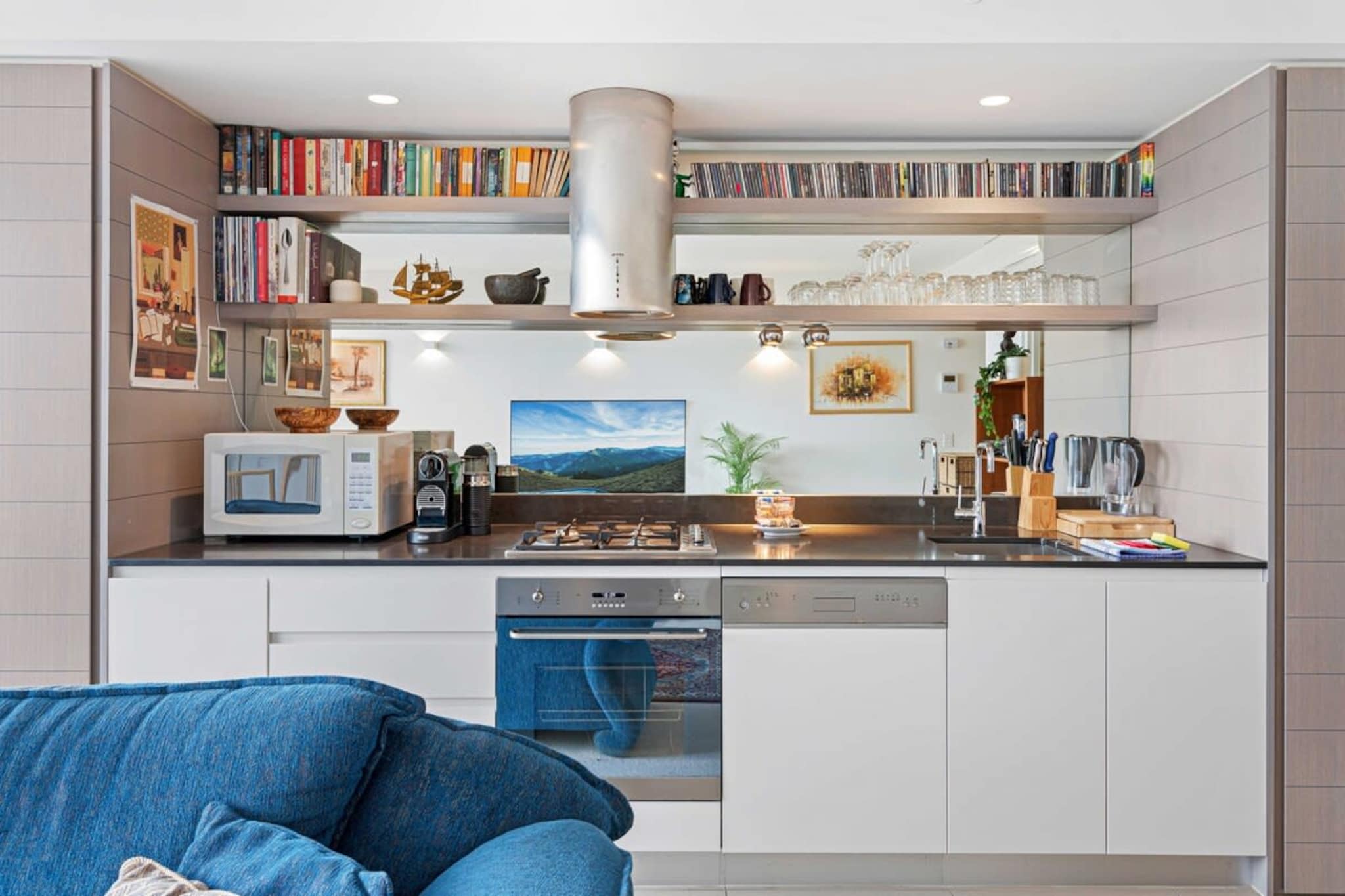 Discover Melbourne’s iconic suburbs in this eclectic 1-bed apartment with gorgeous city views. Situated near the Yarra Trail and the local Victoria Gardens Shopping Centre, relish in all the nearby cafes, restaurants, bars and the popular Leadbeater Hotel music venue. Featuring bright interiors, the property includes a balcony with a BBQ and outdoor seating along with access to the on-site pool, gym and rooftop bbq facilities. For those seeking a homely base to explore the city, this is for you.
The space
This chic 1-bedroom, 1-bathroom apartment offers the perfect blend of style and convenience. The contemporary interiors are beautifully designed with elegant decor and high-end furnishings, creating a comfortable and sophisticated living space. The apartment features a queen bedroom with blackout blinds and air conditioning for year-round comfort. Enjoy the generous balcony, complete with a BBQ and outdoor dining area, where you can take in stunning views of the city. On-site parking adds to the ease of living, and the building includes fantastic communal amenities such as a gym and a pool. Ideally situated near the Yarra Trail and Victoria Gardens Shops, with close access to public transport, this apartment provides a seamless lifestyle in a prime location.
 
Living room
- Couch seats 3 people
- TV with free-to-air, streaming services (guests to use their own credentials) and sound bar available.
 
Kitchen & Dining Area
- Fully equipped with cookware, blender, utensils and cutlery
- Oven and gas stovetop
- Dining area seats 2 people
 
Bathroom & Laundry
- Laundry room available with washer only
- Travel essentials, towels and hairdryer provided
 
Amenity Notes:
- One parking spot available
- Air conditioning in living area
- Electric blanket in bedroom
- iPhone chargers in bedroom
- WIFI
- Communal pool & gym for use
- Private balcony with outdoor seating and BBQ
Local area description
Abbotsford is a vibrant Melbourne suburb known for mixing industrial parks with green public spaces and charming residential areas. Home to a thriving cafe and pub culture, the suburb is popular among many families and creative types alike. Home-converted factories, charming cafes, the popular Johnston St bars, home markets, creative workshops and artists’ studios, relish in the vibrant local atmosphere. Nestled along the Yarra River, the suburb offers extensive parks, bushwalks and reserves to explore. An energetic hub of activity Abbotsford is an idyllic gem in Melbourne’s inner suburbs.