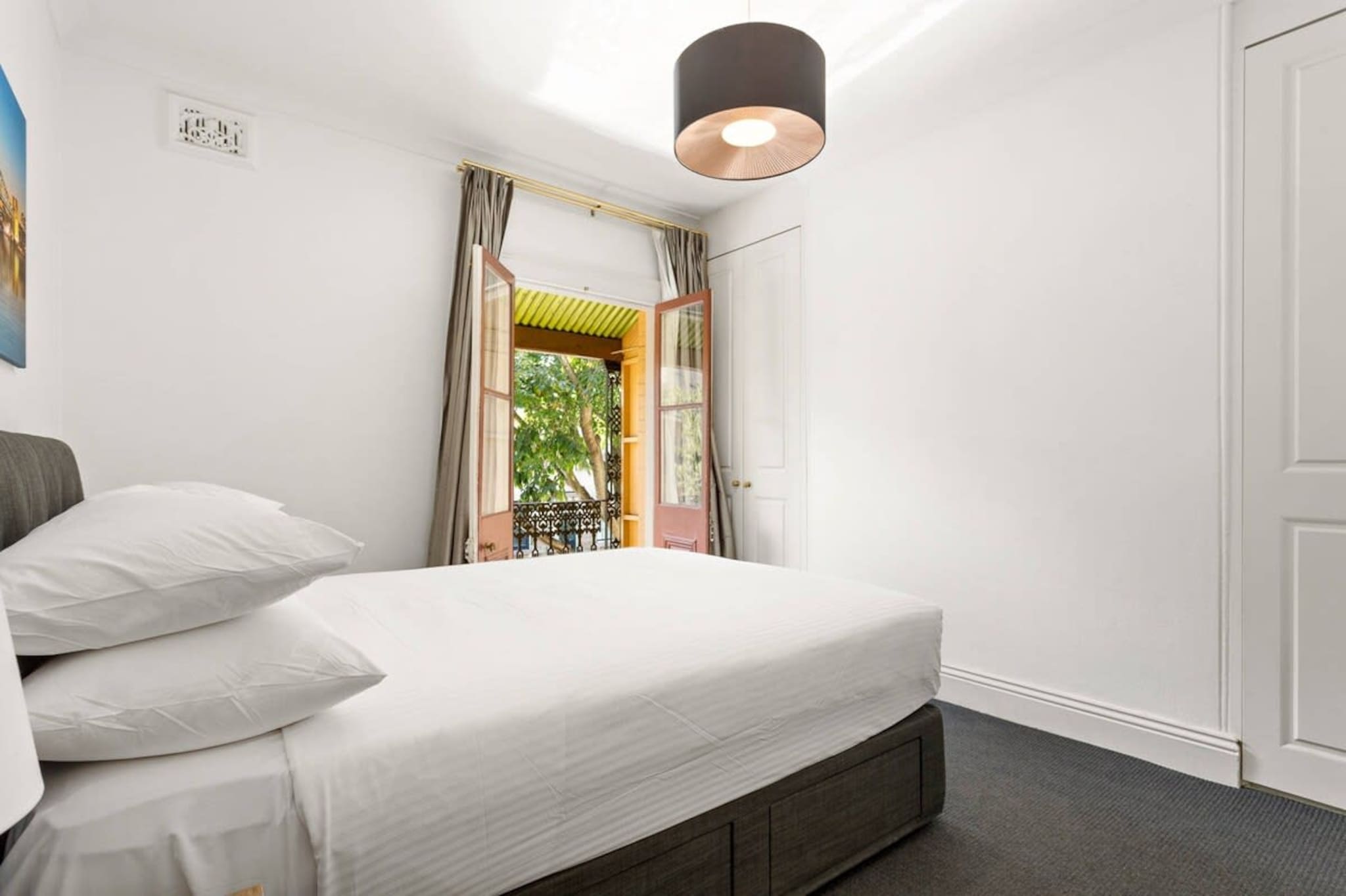 Immerse yourself in Sydneyâ€™s stunning inner-city in this traditional 2-bed terrace house by the CBD. Featuring a heritage design, this elevated property boasts a balcony with skyline views and a courtyard with outdoor seating available. Situated within walking distance from Barangaroo, The Rocks and Sydneyâ€™s CBD. Relish in the city's numerous cafes, restaurants, bars, clubs, theatres, parks and more all moments from the house. For those wanting an unforgettable trip, this is the place for you.

The space
Meticulously designed, this original terrace house offers chic interiors combined with refined furnishings to create a welcoming atmosphere. Featuring an open-plan living area, modern appliances, a sleek kitchen, a polished bathroom, beautiful bedrooms, a backroom study nook, a private balcony with skyline views and a courtyard with outdoor seating. Enjoy this propertyâ€™s pristine atmosphere and gorgeous interiors equipped with everything you need for a memorable trip.
 
General
- Chic 2-bedroom, 1-bathroom house
- WI-FI
- Close to public transport
- Blackout blinds available
- Portable fans available
- Backroom study nook
- Gorgeous balcony with views of the skyline
- Private courtyard with outdoor seating
- Modern interiors with bright decor and modern furnishings
- Great location moments from Barangaroo, the Rocks and the CBD
- Heaters provided
 
Bedroom & bathroom
- Bedroom 1: 1x Queen Bed
- Bedroom 2: 1x Double Bed
- Portable fans
- Ceiling fans
- Blackout blinds
 
Living Room
- Gorgeous couch, armchair and coffee table
- TV with streaming options
- Portable fans
- 4-seater dining table
 
Kitchen
- Fully stocked with appliances
- Kettle, toaster, coffee machine and microwave
- Oven and gas stovetop
- Dishwasher
 
Bathroom & Laundry
- Sleek bathroom available
- Travel essentials, towels and hairdryer provided
- Laundry room available with washing machine and dryer
 
Points of Interest
Observatory Hill lookout and Park - 2 minutes (260m) walk away
Barangaroo Reserve and Marrinawi Cove - 5 minute (400m) walk away
Argyle Street Shops and Dining Strip - 7 minutes (550m) walk away
Local area description
Millers Point is a thriving inner-city suburb of Sydney famous for being the home of the Sydney Observatory. Neighbouring the Rocks, Barangaroo and the city's CBD, Millers Point offers a vibrant array of attractions to experience all in and around this iconic suburb. Offering local cafes, boutique stores, bustling restaurants, dive bars, bustling pubs and even a casino, the local atmosphere is teaming with activity and adventure. Additionally, the suburb offers incredibly scenic lookout spots overlooking the iconic harbour. With its central location, bustling atmosphere and attractions, Millers Point is the perfect inner city spot.
House rules
You are staying in a friendly and peaceful neighbourhood and we kindly ask you to respect the community and your surrounding neighbours. The following strict House Rules apply:
 
- No loud noise between 10 pm and 8 am
- No parties or antisocial behaviour
- No additional people are to access the property without our prior approval
- No pets are allowed in the property without approval
- No smoking is allowed at any times
- If you break something, please let us know
- To help protect all floor coverings do not wear any shoes inside the property
 
Please be aware that excessive noise such as amplified music, vocals or screaming or anti-social behaviour in the property or common areas can cause neighbours to complain to us, the Building Manager, Council Rangers or Police.
 
IMPORTANT: Any breach of the House Rules may lead to a $500 fine plus compensation for any cost/damage created and immediate eviction of the property.
 
Finally, when checking out, we kindly ask you for the following:
 
- Please leave all beds unmade
- Please clean up your dishes and put them away
- In case you have rearranged furniture, please put it back to the original location
- Please take out the rubbish and remember to use the right bins
- Please ensure all appliances, A/C and lights are off and doors and windows are closed
Interaction with guests
Welcome to MadeComfy! Our local team curates stays in exceptional Australian & New Zealand properties, ensuring style, comfort, and prime locations for discerning guests. We prioritise your needs to provide a memorable home-away-from-home experience. Explore our digital guidebooks for local recommendations, and don't hesitate to contact us throughout your stay. We're here to ensure your comfort â€“ enjoy your stay with MadeComfy.
Notes
- For your comfort, this property is prepared with professional-grade hotel-style linen, including a three-sheet setup, ensuring a fresh and hygienic sleep experience.
- There is no on-site parking. 2 hours of limited street parking available. Walsh Bay, Barangaroo Wilson paid parking options available nearby.
- There are stairs inside the property. The stairway is narrow so can be difficult for children or anyone with mobility issues.
- There are no heaters
- As a bustling area, the local atmosphere is teaming with activity and adventure, and some noise is expected
 
 
Extra Services:
- Early check-in: Our standard check-in is at 3 pm. To guarantee early access to the property we suggest booking the night before if available. Otherwise, early check-in is subject to availability from the night before at an additional cost.
- Late check-out: Our standard check-out is at 10 am. To guarantee a later check-out of the property we suggest booking an additional night if available. Otherwise, a late check-out is subject to availability from the night before to an additional cost.
- Baggage: For security reasons, we are unable to receive or to keep unattended baggage before check-in or after check-out
- We provide a small welcome amenity pack to get your stay started
- No pets allowed.
- This booking is protected with coverage for lost baggage and emergency medical expenses, provided by Travel Support with claim upto 500 AUD (T&C Applies). For more details reach out to Guest Support team post booking.
Access description
- To access the property, use the front door right on the street. Youâ€™ll have access to the entire property when you stay here, so it will feel like your own home.
- The keys will be left in a lockbox attached to the front door security gate.
- There are narrow stairs inside the property.
Getting around
Public transport
The property is situated near numerous bus stops operating trips to Watsons Bay, Central, Walsh Bay and City. Additionally, the nearby Wynyard station operates trips along all major city lines. While ferries leaving from Barangaroo operate trips to Parramatta, Sydney Olympic Park, Circular Quay, Pyrmont Bay, and Blackwattle Bay.
 
Ride sharing
There is plenty of taxi and ride-sharing options readily available throughout Millers Point.
 
Points of Interest
Observatory Hill lookout and Park - 2 minutes (260m) walk away.
Barangaroo Reserve and Marrinawi Cove - 5 minute (400m) walk away.
Argyle Street Shops and Dining Strip - 7 minutes (550m) walk away.
 
Getting there
The property is approximately a 30-minute drive from Sydney Airport.