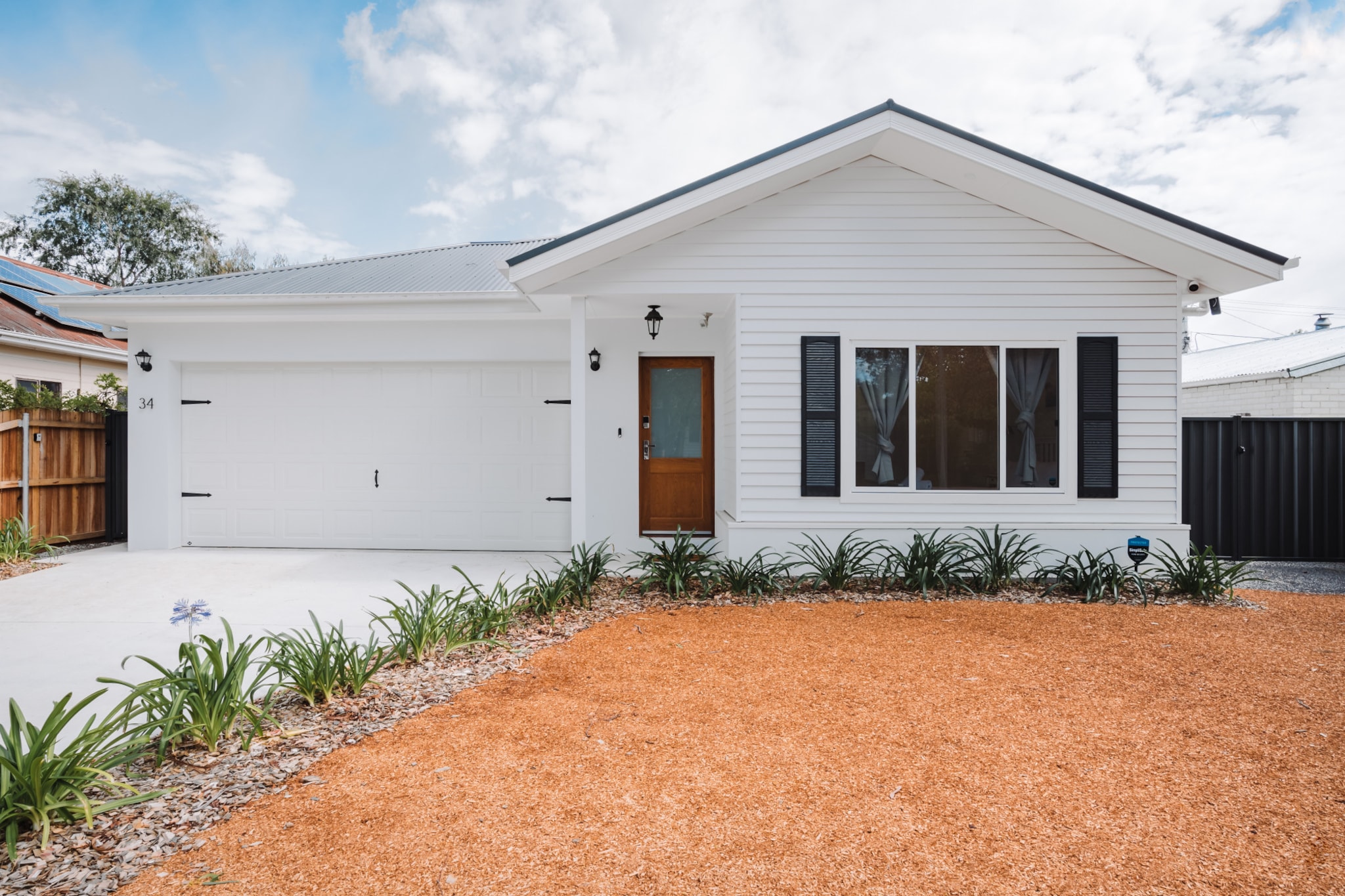 Relax and unwind in Canberra’s peaceful suburbia in this exquisitely spacious 3-bed home. Featuring stunningly refined interiors relish in the property's atmosphere complete with a shaded patio and a gorgeous alfresco dining area. Situated metres from local parklands and shops appreciate the property’s convenient location only a short drive into the city centre. An elegant home prime for those seeking a peaceful base to explore the city, what more could you ask for?
The space
Meticulously designed, this elegant house includes premium interiors combined with an abundance of natural light to create an open and welcoming atmosphere. Featuring an open-plan living area, modern appliances, a sleek kitchen with counter seating, a study room, polished bathrooms, beautiful bedrooms, a shaded patio with outdoor seating and a charming alfresco dining space with additional seating. Appreciate for yourself this property’s pristine atmosphere and gorgeous interiors equipped with everything you’d need for a memorable trip.
 
General
- Premium 3-bedroom, 2-bathroom house
- Wi-Fi is available
- Close to public transport
- On-site parking available (4 spots)
- Blackout blinds
- A/C and heating
- Charming shaded back patio with outdoor seating
- Spacious backyard with an elegant alfresco dining area
- Modern interiors with contemporary decor and furnishings
- Great location moments from local shops, parks and the city centre
- Self check-in
 
Bedroom
- Bedroom 1: 1x Queen Bed with a WIR and an ensuite
- Bedroom 2: 1x Queen Bed
- Bedroom 3: 1x Double Bed
- Blackout blinds
- A/C and heating
 
Living Room
- Plush couches, armchairs and a coffee table
- TV with free-to-air and streaming services
- A/C and heating
- Blackout blinds
- 6-seater dining table
 
Kitchen
- Fully equipped with cookware, utensils and cutlery
- Toaster, microwave and coffee machine
- Oven and gas stovetop
- Dishwasher
- 4-seater counter area
 
Bathroom & Laundry
- Sleek bathroom
- Travel essentials, towels and hairdryer provided.
- Laundry room available with washer and dryer.
 
Points of Interest
Narrabundah Oval Reserve - 1 minute (90m) walk away.
Narrabundah Shops - 2 minutes (180m) walk away.
Kingston Foreshore Bar Strip - 5 minutes (2.8km) drive away.
