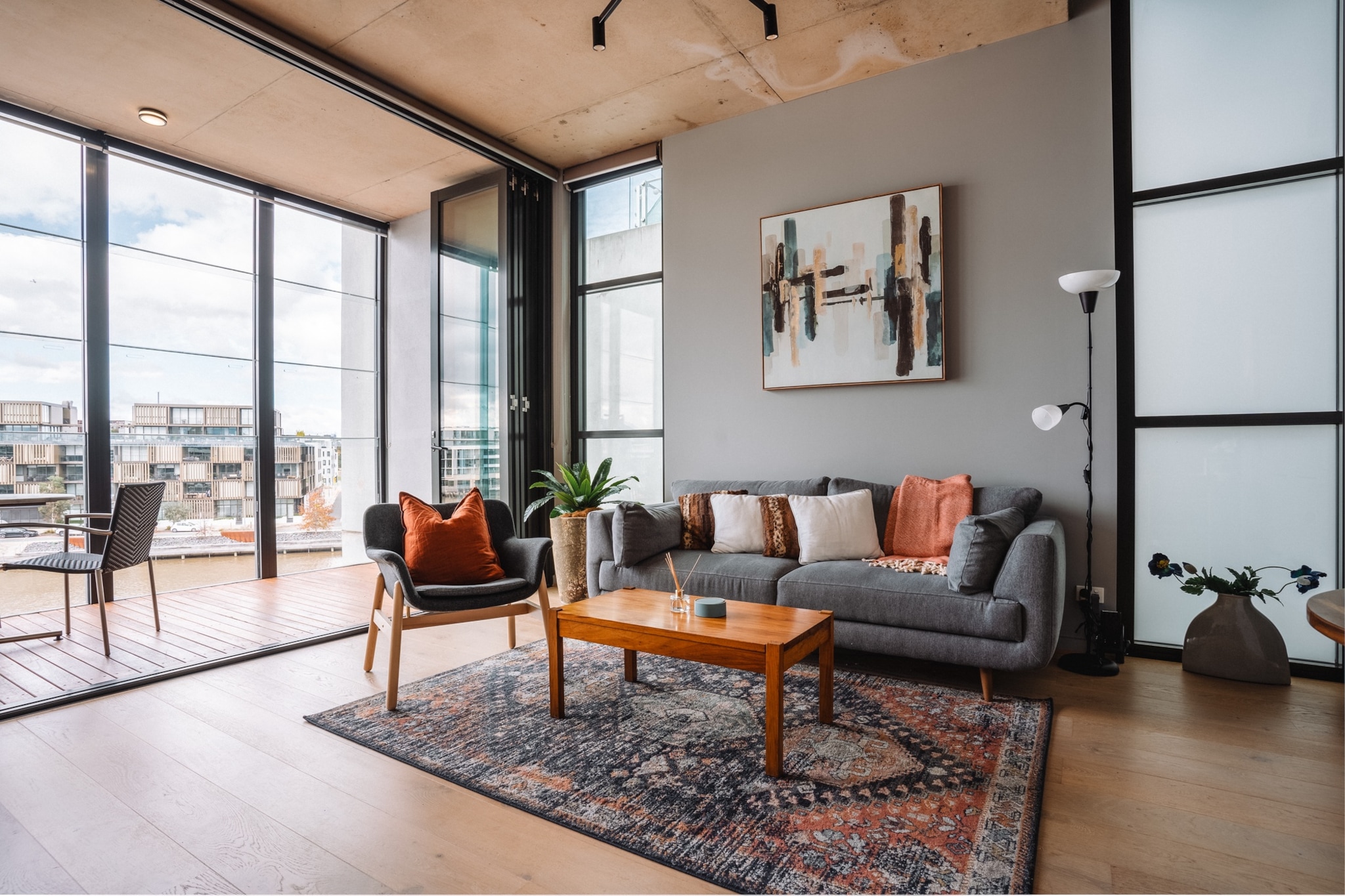 Relish in the lively side of Canberra in this stunning 1-bed apartment above the popular Kingston foreshore with unobstructed water views. Featuring sleek industrial interiors this contemporary apartment offers a pristine atmosphere with gorgeous views. Situated above the Kingston foreshore dining precinct the property boasts proximity to nearby shops, markets and parks. For couples wanting to treat themselves to an idyllic waterside stay near the bustling city, this is the spot for you.
The space
Meticulously designed, this incredible apartment offers bespoke contemporary interiors accentuated by an abundance of natural light. Featuring an open-plan living area, modern appliances, a sleek kitchen, a polished bathroom, a generous bedroom, and an enclosed balcony. Wake up to a stunning water view from the bedroom, experience for yourself this property’s pristine atmosphere and gorgeous interiors equipped with everything you’d need for an unforgettable stay.
 
General
- Chic 1-bedroom, 1-bathroom apartment
- Wi-Fi is available
- Close to public transport
- On-site parking is available
- A/C, heating and portable fan available
- Common room area available for use
- An enclosed balcony with outdoor seating and views
- Modern interiors with contemporary decor and furnishings
- Great location near the local shops, markets and dining precinct
- Self check-in
 
Bedroom
- Bedroom 1: 1x Queen bed, wardrobe and additional storage unit under TV
- Portable heater and fans
- Vacuum cleaner, DVD player and ‘Smart’ TV
- Blockout blinds
 
Living room
- Plush couch, armchair and coffee table
- TV with free-to-air and streaming options
- 2-seater dining table
- Blockout blinds
- Vacuum cleaner, DVD player and ‘Smart’ TV
- A/C and heating
 
Kitchen
- Fully equipped with cookware, utensils, cutlery and crockery
- Toaster, kettle, coffee machine and microwave
- Oven and an electric stovetop
- Dishwasher available
 
Bathroom & Laundry
- Sleek bathroom available
- Travel essentials, towels and a hairdryer are provided
- The laundry room is available with a washing/dryer combo
- Iron, ironing board and cloth drying rack are available
 
Points of Interest
- Kingston Foreshore Dining Precinct - 1 minute (60m) walk away
- Old Bus Depot Markets and Canberra Glassworks - 6 minutes (500m) walk away
- Kingston Shopping Precinct with various specialty shops and large shopping centre - 7 minutes (600m) walk away
- Lake cruises and self-drive boating available at your doorstep
- Norgrove Park - 1-minute walk
- Train Station - 12-minute walk
- Airport - 11 minutes drive
Local area description
Kingston is a vibrant and trendy Canberra neighbourhood that borders the famous Lake Burley Griffin. Known for its contemporary foreshore with numerous cafes, restaurants, bars and boutique shops, take your pick of stores to explore. Kingston is also home to the famous Old Bus Depot Markets which offer an array of weekend vendors selling locally sourced goods and produce. Meanwhile, next door drop into Canberra Glassworks, which offers exhibitions and workshops. Peppered with parks and lakeside walks, all situated a short distance from the CBD, engross yourself in the Kingston atmosphere.
House rules
You are staying in a friendly and peaceful neighbourhood and we kindly ask you to respect the community and your surrounding neighbours. The following strict House Rules apply:
- No loud noise between 10 pm and 8 am
- No parties or antisocial behaviour
- No additional people are to access the property without our prior approval
- No pets are allowed in the property
- No smoking is allowed at any times
- If you break something, please let us know
- To help protect all floor coverings do not wear any shoes inside the property
 
Please be aware that excessive noise such as amplified music, vocals or screaming or anti-social behaviour in the property or common areas can cause neighbours to complain to us, the Building Manager, Council Rangers or Police.
 
IMPORTANT: Any breach of the House Rules may lead to a $500 fine plus compensation for any cost/damage created and immediate eviction of the property.
 
Finally, when checking out, we kindly ask you for the following:
- Please leave all beds unmade
- Please clean up your dishes and put them away
- In case you have rearranged furniture, please put it back to the original location
- Please take out the rubbish and remember to use the right bins
- Please ensure all appliances, A/C and lights are off and doors and windows are closed
Interaction with guests
Welcome to MadeComfy! Our local team curates stays in exceptional Australian & New Zealand properties, ensuring style, comfort, and prime locations for discerning guests. We prioritise your needs to provide a memorable home-away-from-home experience. Explore our digital guidebooks for local recommendations, and don't hesitate to contact us throughout your stay. We're here to ensure your comfort – enjoy your stay with MadeComfy.
Notes
- For your comfort, this property is prepared with professional-grade hotel-style linen, including a three-sheet setup, ensuring a fresh and hygienic sleep experience.
- To access the on-site parking enter the carpark entrance located on the left-hand side of the building.
- There are no stairs inside or outside the property.
- The dining precinct below the apartment can get busy on weekends.
- Building works are happening at the property. Scaffolding has been put up outside of the bedroom window. Tradesmen are expected between 7 am and 12 pm.
 
Extra Services:
- Early check-in: Our standard check-in is at 3 pm. To guarantee early access to the property we suggest booking the night before if available. Otherwise, early check-in is subject to availability from the night before at an additional cost.
- Late check-out: Our standard check-out is at 10 am. To guarantee a later check-out of the property we suggest booking an additional night if available. Otherwise, a late check-out is subject to availability from the night before to an additional cost.
- Baggage: For security reasons, we are unable to receive or to keep unattended baggage before check-in or after check-out
- We provide a small welcome amenity pack to get your stay started
- No pets are allowed in the property
- This booking is protected with coverage for lost baggage and emergency medical expenses, provided by Travel Support with claim upto 500 AUD (T&C Applies). For more details reach out to Guest Support team post booking.
Access description
- You’ll have access to the entire property when you stay here, so it will feel like your own home.
- There are no stairs inside or outside the property.
- The keys will be left in a lockbox. We will send you the access code 3 days prior to your arrival through the booking portal.
Getting around
Public transport
The property is near three separate bus stops, on Wentworth Ave and Eyre St. These stops operate routes to Fyshwick, City, City West, Fraser and Queanbeyan. Meanwhile, the Canberra Railway Station operates trips via the Southern NSW line to Central Station in Sydney.
 
Ride sharing
There is plenty of taxi and ride-sharing options readily available throughout Canberra.
 
Points of Interest
Kingston Foreshore Dining Precinct - 1 minute (60m) walk away
Old Bus Depot Markets and Canberra Glassworks - 6 minutes (500m) walk away
Kingston Shopping Precinct with various specialty shops and large shopping centre - 7 minutes (600m) walk away
Lake cruises and self-drive boating available at your doorstep
Norgrove Park - 1-minute walk
Train Station - 12-minute walk
Airport - 11 minutes drive
 
Getting there
The property is approximately a 10-minute drive from Canberra Airport or a roughly 3-hour drive from Sydney’s CBD.