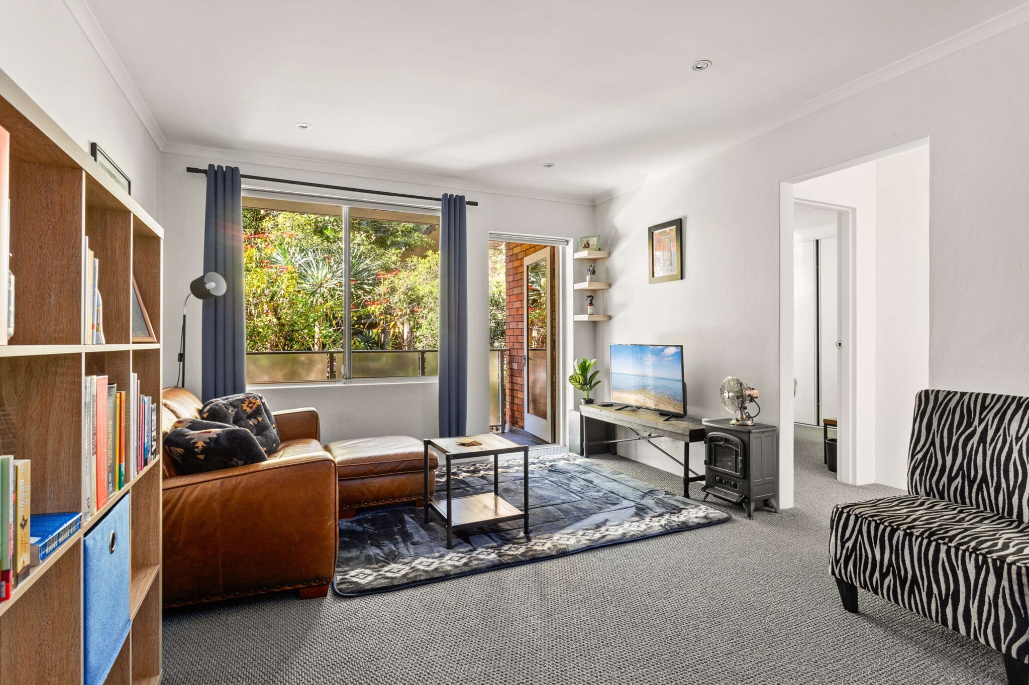Experience the quiet charm of Sydney’s Lower North Shore in this beautifully peaceful 2-bed apartment. Featuring sleek modern interiors this pristine property offers a perfectly homely vibe complete with a private balcony and outdoor seating. Situated mere moments from numerous local cafes, parks, restaurants, shopping centres, theatres and the vibrant city centre. For those wanting a tranquil base to experience Sydney, look no further.
The space
Gorgeously designed this incredible apartment includes contemporary decor coupled with an abundance of natural light. Offering an open-plan living, a sleek kitchen, modern appliances, a polished bathroom, gorgeous bedrooms and a private balcony with outdoor seating. Experience for yourself this property’s perfectly curated atmosphere with everything you’d need for an unforgettable stay.
 
General
- Chic 2-bedroom, 1-bathroom apartment
- WI-FI s available
- On-site parking is available (1 spot & visitor parking)
- Close to public transport
- Cosy balcony with outdoor seating
- Modern interiors with contemporary interiors and furnishings.
- Great location near the local parks, cafes, shops, restaurants and city.
- This property does not have air-conditioning
 
Bedroom
- Bedroom 1: 1x King bed
- Bedroom 2: 1x Single bed with a study nook
- The second bedroom does not have blackout blinds
- Portable fans and heaters
 
Living Room
- Plush couch, armchair and coffee table
- TV with free-to-air and streaming options available (use your own account)
- Blackout blinds are available
- 4-seater dining table
 
Kitchen
- Fully equipped with cookware, utensils and cutlery
- Toaster, kettle and microwave are available
- Oven and an induction stovetop available
- Dishwasher
 
Bathroom & Laundry
- Sleek bathroom
- Laundry room available with a washer and dryer
- Travel essentials, towels and a hairdryer are provided.