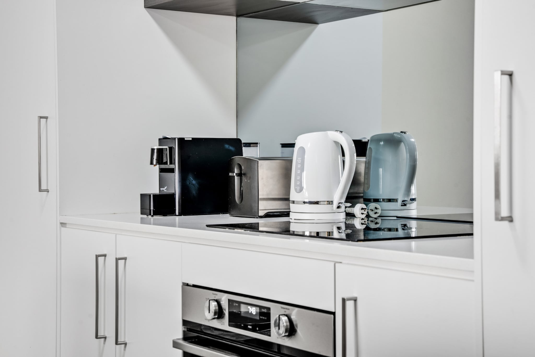 Relish in the pristine Greenway atmosphere in this modest 2-bed apartment by the local shopping centre. Featuring modern interiors this gorgeous apartment has a charming balcony with outdoor seating available. Situated metres from local cafes, restaurants, shopping centre, lakeside trails and a short drive from the city centre. For those seeking a thriving base outside of the city’s heart, this property is perfect for you.

The space
Impeccably designed, this contemporary apartment offers chic interiors accentuated by an abundance of natural light. Featuring an open-plan living area, a sleek kitchen, modern appliances, a polished bathroom, pristine bedrooms and a gorgeous balcony with outdoor seating available. Experience for yourself this property’s perfectly curated atmosphere with everything you’d need for an unforgettable stay.
 
General
- Chic 2-bedroom, 1-bathroom apartment
- Wi-Fi is provided
- Close to public transport
- On-site parking available
- Blackout blinds
- A/C and heating available in the living room
- Beautiful balcony with outdoor dining and seating available
- Modern interiors with contemporary interiors and furnishings
- Incredible location by local cafes, restaurants and shopping centre
- Self check-in
 
Bedroom
- Bedroom 1: 1x King bed
- Bedroom 2: 1x King bed
- Blackout blinds
 
Living Room
- Plush couch, armchairs and coffee table
- TV with free-to-air channels
- A/C and heater are available
- Blackout blinds are available
- Study desk
- 4-seater dining table
 
Kitchen
- Fully equipped with cookware, utensils and cutlery
- Toaster, kettle, coffee machine and microwave
- Oven and an induction stovetop
- Dishwasher
 
Bathroom & Laundry
- Sleek bathroom is available.
- Laundry unit with a washer and dryer
- Travel essentials, towels and a hairdryer are provided.
 
Points of Interest
South Point Tuggeranong - 1 minute (65m) walk away.
Tuggeranong Park, Beach and Leisure Centre - 2 minutes (120m) walk away.
Homework Tuggeranong Shops - 6 minutes (550m) walk away.
Local area description
Greenway is a bustling built-up Canberra suburb located outside the city centre, in the city’s southern Tuggeranong district. Comprising mainly of thriving shopping streets the suburb is also home to numerous shopping malls, generous reserves, a charming lake, walking trails, sports venues and modest beaches to relish in the vibrant local atmosphere. A hub of activity, Greenway acts as a thriving modern suburb busting at the seams with numerous shopping centres, natural beauty and a gorgeous lake, all tucked away in the city’s south.
House rules
You are staying in a friendly and peaceful neighbourhood and we kindly ask you to respect the community and your surrounding neighbours. The following strict House Rules apply:
- No loud noise between 10 pm and 8 am
- No parties or antisocial behaviour
- No additional people are to access the property without our prior approval
- No pets are allowed in the property without approval
- No smoking is allowed at any times
- If you break something, please let us know
 
- To help protect all floor coverings do not wear any shoes inside the property
 
Please be aware that excessive noise such as amplified music, vocals or screaming or anti-social behaviour in the property or common areas can cause neighbours to complain to us, the Building Manager, Council Rangers or Police.
 
IMPORTANT: Any breach of the House Rules may lead to a $500 fine plus compensation for any cost/damage created and immediate eviction of the property.
 
Finally, when checking out, we kindly ask you for the following:
- Please leave all beds unmade
- Please clean up your dishes and put them away
- In case you have rearranged furniture, please put it back to the original location
- Please take out the rubbish and remember to use the right bins
- Please ensure all appliances, A/C and lights are off and doors and windows are closed.
Interaction with guests
Welcome to MadeComfy! Our local team curates stays in exceptional Australian & New Zealand properties, ensuring style, comfort, and prime locations for discerning guests. We prioritise your needs to provide a memorable home-away-from-home experience. Explore our digital guidebooks for local recommendations, and don't hesitate to contact us throughout your stay. We're here to ensure your comfort – enjoy your stay with MadeComfy.
Notes
- For your comfort, this property is prepared with professional-grade hotel-style linen, including a three-sheet setup, ensuring a fresh and hygienic sleep experience.
- To access the on-site parking, enter via Cowlishaw St and tap the swipe card on the sensor under the intercom. Drive up to the sensor to your right-hand side near the second roller gate; tap the swipe card on the sensor on the side and drive all the way down through the ramp then turn left. Then find carspot 114.
- There are no stairs outside or inside the property.
- The unit is only available via a lift.
 
 
Extra Services:
- Early check-in: Our standard check-in is at 3 pm. To guarantee early access to the property we suggest booking the night before if available. Otherwise, early check-in is subject to availability from the night before at an additional cost.
- Late check-out: Our standard check-out is at 10 am. To guarantee a later check-out of the property we suggest booking an additional night if available. Otherwise, a late check-out is subject to availability from the night before to an additional cost.
- Baggage: For security reasons, we are unable to receive or to keep unattended baggage before check-in or after check-out
- We provide a small welcome amenity pack to get your stay started
- - Pets allowed upon approved requests, additional fees apply
- This booking is protected with coverage for lost baggage and emergency medical expenses, provided by Travel Support with claim upto 500 AUD (T&C Applies). For more details reach out to Guest Support team post booking.
Access description
- The keys will be left in a lockbox onsite. We will send you the access code 3 days prior to your arrival through the booking portal.
- The property is located in Abode Hotel. The room number is 219.
- You’ll have access to the entire property when you stay here, so it will feel like your own home.
- There are no stairs outside or inside the property.
Getting around
Public transport
From the nearby bus terminal bus routes operate to Woden, Chisholm Loop, Lanyon, Richardson Loop, Calwell and Belconnen.
 
Ride sharing
There is plenty of taxi and ride-sharing options readily available throughout Canberra. However, we suggest pre-booking due to low availability.
 
Points of Interest
South Point Tuggeranong - 1 minute (65m) walk away.
Tuggeranong Park, Beach and Leisure Centre - 2 minutes (120m) walk away.
Homework Tuggeranong Shops - 6 minutes (550m) walk away.
 
Getting there
The property is approximately a 25-minute drive from Canberra airport or a 3-hour 30-min drive from Sydney’s CBD.