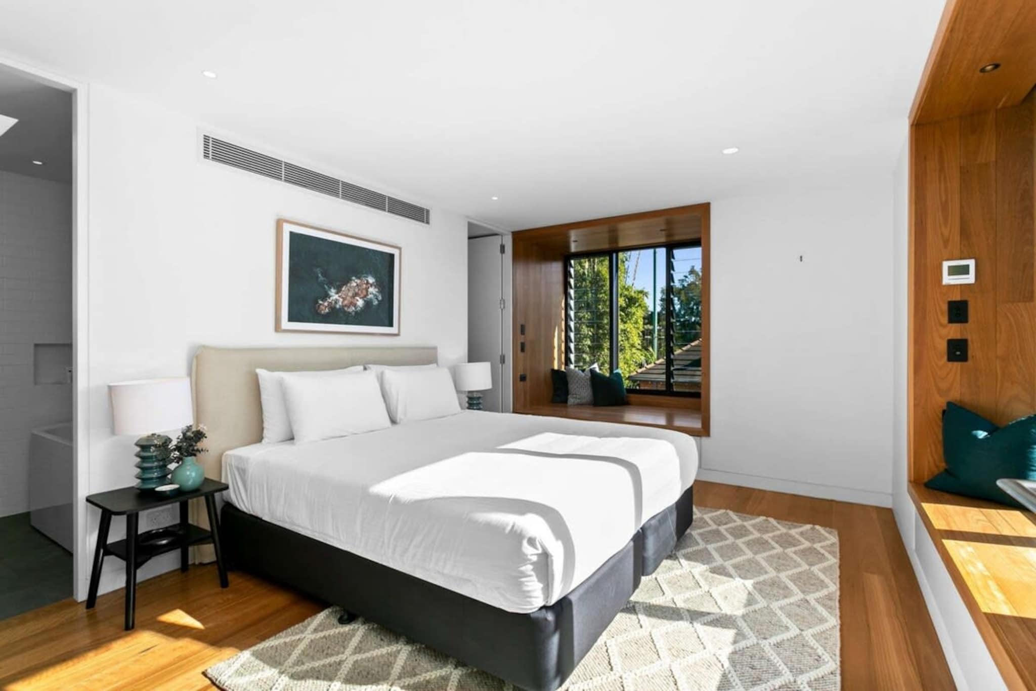 Relish in the iconic Manly atmosphere in this impeccable 3-bed home near the seaside. Featuring elegantly modern interiors the property boasts an architectural design, sunlit rooms and a generous outdoor courtyard with outdoor dining. Situated an easy stroll from the picturesque Queenscliff Beach, indulge in the idyllic coastal atmosphere near local parks, cafes, restaurants and the Manly Corso. For those with a taste for the luxurious, this incredible property is perfect for your next trip.

The space
Architecturally designed this meticulously curated home boasts uniquely contemporary decor coupled with an abundance of natural light. Offering a stunning open-plan living area, a sleek kitchen with counter seating, premium appliances, polished bathrooms, gorgeous bedrooms, automatic blinds and a generous courtyard with outdoor dining. Experience for yourself this property’s perfectly curated atmosphere with everything you’d need for an unforgettable stay.
 
General
- Elegant 3-bedroom, 3-bathroom house
- WI-FI is available
- On-site parking available (2 spots)
- Close to public transport
- Pet friendly
- Ducted A/C is available in every room
- Automatic blinds are available downstairs
- Pristine courtyard with lush outdoor dining available
- Premium interiors with contemporary interiors and furnishings
- Great location near the local parks, cafes, shops, and stunning beachside
 
Bedroom
- Bedroom 1: 1x King bed with a walk-in robe and ensuite
- Bedroom 2: 1x Queen bed with an ensuite
- Bedroom 3: 2x Single bed
- Automatic blinds are available
- Ducted A/C in all bedrooms
 
Living Room
- Leather couch, armchairs and coffee table
- TV with free to air channels
- Ducted A/C are available throughout
- Window sill seating area available
- Automatic blinds are available
- 6-seater dining table
 
Kitchen
- Fully equipped with cookware, utensils and cutlery
- Toaster, kettle, coffee machine and microwave
- Oven and a gas stovetop
- Dishwasher
- 3-seater counter area
 
Bathroom & Laundry
- Sleek bathrooms
- Laundry room available with a washer and dryer
- Travel essentials, towels and a hairdryer are provided
 
Points of Interest
Swim Centre and Sports Reserve - 4 minutes (260m) walk away.
Pittwater Road Dining Strip - 4 minutes (300m) walk away.
Queenscliff Beach- 9 minutes (700m) walk away.
Manly Beach-11 minutes (850m) walk away.
Local area description
Manly is one of Sydney’s most iconic suburbs, famous for its beach culture, bustling Corso, nightlife and restaurant scene. Situated at the gateway to the Northern beaches, yet still only a short distance from Sydney’s CBD, Manly retains both a cosmopolitan and relaxed coastal vibe. Containing both ocean and harbour beaches, rock pools and bush walks, Manly has nature on full display. All within a short distance to its famous shopping precinct, with numerous famous pubs, restaurants and attractions. A bustling centre of music, food and outdoor activities, Manly caters to and welcomes all to its iconic suburb.
House rules
You are staying in a friendly and peaceful neighbourhood and we kindly ask you to respect the community and your surrounding neighbours. The following strict House Rules apply:
 
- No loud noise between 10 pm and 8 am
- No parties or antisocial behaviour
- No additional people are to access the property without our prior approval
- No smoking is allowed at any times
- If you break something, please let us know
- To help protect all floor coverings do not wear any shoes inside the property
 
Please be aware that excessive noise such as amplified music, vocals or screaming or anti-social behaviour in the property or common areas can cause neighbours to complain to us, the Building Manager, Council Rangers or Police.
 
IMPORTANT: Any breach of the House Rules may lead to a $500 fine plus compensation for any cost/damage created and immediate eviction of the property.
 
Finally, when checking out, we kindly ask you for the following:
 
- Please leave all beds unmade
- Please clean up your dishes and put them away
- In case you have rearranged furniture, please put it back to the original location
- Please take out the rubbish and remember to use the right bins
- Please ensure all appliances, A/C and lights are off and doors and windows are closed
Interaction with guests
Welcome to MadeComfy! Our local team curates stays in exceptional Australian & New Zealand properties, ensuring style, comfort, and prime locations for discerning guests. We prioritise your needs to provide a memorable home-away-from-home experience. Explore our digital guidebooks for local recommendations, and don't hesitate to contact us throughout your stay. We're here to ensure your comfort – enjoy your stay with MadeComfy.
Notes
- For your comfort, this property is prepared with professional-grade hotel-style linen, including a three-sheet setup, ensuring a fresh and hygienic sleep experience.
- To access the on-site parking, use the remote to open the sliding electric gate and drive through. Press the button a second time to close the gate.
- There are stairs inside and outside the property.
- To control the blinds, please use a remote. The remote for the downstairs blinds is located in the top drawer of the kitchen and the remote to control the upstairs blinds is located in the cabinet at the top of the stairs.
- Medium and smaller dogs are allowed. Any stays with pets will incur an additional cleaning fee.
 
Extra Services:
- Early check-in: Our standard check-in is at 3 pm. To guarantee early access to the property we suggest booking the night before if available. Otherwise, early check-in is subject to availability from the night before at an additional cost.
- Late check-out: Our standard check-out is at 10 am. To guarantee a later check-out of the property we suggest booking an additional night if available. Otherwise, a late check-out is subject to availability from the night before to an additional cost.
- Baggage: For security reasons, we are unable to receive or to keep unattended baggage before check-in or after check-out
- We provide a small welcome amenity pack to get your stay started
- This booking is protected with coverage for lost baggage and emergency medical expenses, provided by Travel Support with claim upto 500 AUD (T&C Applies). For more details reach out to Guest Support team post booking.
Access description
- You’ll have access to the entire property when you stay here, so it will feel like your own home.
- The keys will be left in a lockbox.
- There are stairs inside and outside the property.
Getting around
Public transport
The nearest bus stop operates trips to Palm Beach, Avalon and Manly.
 
Ride sharing
There is plenty of taxi and ride-sharing options readily available throughout Manly.
 
Points of Interest
Swim Centre and Sports Reserve - 4 minutes (260m) walk away.
Pittwater Road Dining Strip - 4 minutes (300m) walk away.
Queenscliff Beach - 9 minutes (700m) walk away.
 
Getting there
Property is approximately a 40-minute drive to Sydney Airport.