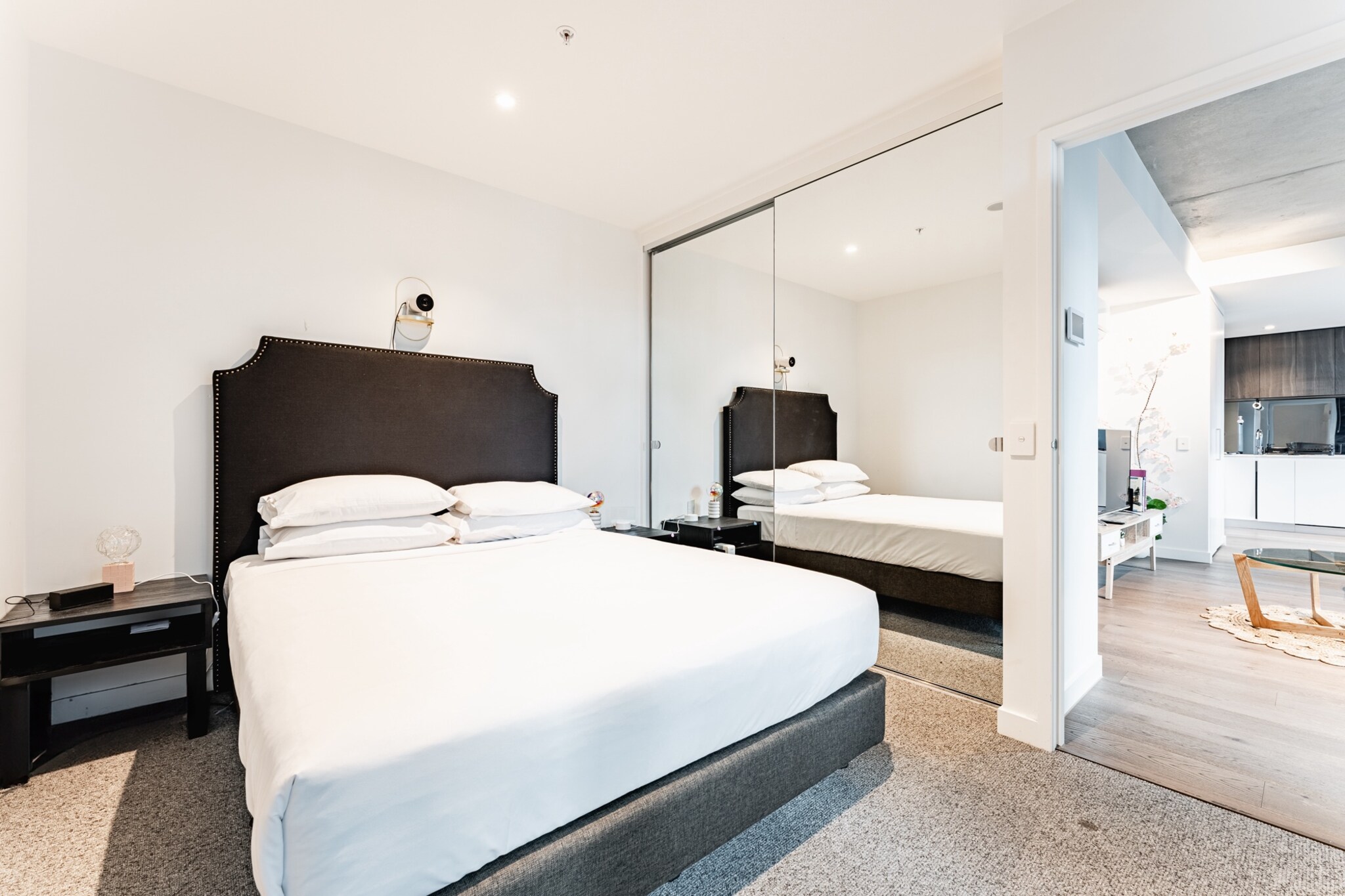 Experience Melbourne like a local from this chic skyscraper 1-bed apartment. With modern interiors and expansive windows, this urban retreat offers fantastic amenities, including a pool and gym. Just a short walk away, you’ll find cultural treasures such as the Melbourne Arts Centre and the National Gallery of Victoria, Federation Square, Royal Botanic Gardens or Queen Victoria Market. This property places you in a prime location at the heart of Melbourne’s dynamic scene.
The space
You'll find that this contemporary 1-bed, 1-bath apartment at the heart of Melbourne is the perfect city escape abode! With floor-to-ceiling windows, the living area is bathed in natural light, and the private balcony with alfresco dining is perfect for relaxing or entertaining. The modern bathroom is designed with a walk-in shower, whilst the bedroom offers built-in robes for storage. Enjoy the convenience of air conditioning and an internal laundry, as well as building amenities that include a rooftop terrace dining area, a gymnasium, a lounge room, and a swimming pool. This property blends modern comfort with exceptional facilities, offering a stylish base for your Melbourne adventure.
 
Living room
- Couch sits 3 people
- TV with free-to-air channels & streaming available (guests to use their own credentials)
- Sofa bed
 
Kitchen & Dining Area
- Fully equipped with utensils and cutlery
- Oven and gas stovetop
- Dining area sits 4 people
 
Bathroom & Laundry
- Laundry room available with washer and dryer
- Travel essentials, towels and hairdryer provided
 
Amenity Notes
- Split A/C (heating + cooling) living area
- Wi-Fi available
- No parking
- Amenity access: private undercover balcony with alfresco dining; communal rooftop terrace dining rooms (level 34), gymnasium, lounge room, terrace and swimming pool (level 12)
Local area description
Southbank is known for its modern and upscale urban living, making it a popular choice for those who want to experience Melbourne's vibrant city life while enjoying the beauty of the Yarra River. The suburb is home to some of Melbourne's most iconic cultural institutions, including the National Gallery of Victoria (NGV) and the Arts Centre Melbourne. Southbank features a diverse array of restaurants, cafes, and bars. The suburb boasts several beautiful parks and green spaces along the river, including the Royal Botanic Gardens, Alexandra Gardens, and Birrarung Marr. These areas offer opportunities for picnicking, jogging, and enjoying outdoor activities. The region is well-connected to Melbourne's public transportation network, with tram services running along St Kilda Road and other major routes. The suburb is also within walking distance of Flinders Street Station, one of Melbourne's main transportation hubs.
House rules
You are staying in a friendly and peaceful neighbourhood and we kindly ask you to respect the community and your surrounding neighbours. The following strict House Rules apply:
 
- No loud noise between 10 pm and 8 am
- No parties or antisocial behaviour
- No additional people are to access the property without prior approval of MadeComfy
- No pets are allowed in the property without approval
- No smoking is allowed at any times
- If you break something, please let us know
- To help protect all floor coverings, do not wear any shoes inside the property
 
Please be aware that excessive noise such as amplified music, vocals or screaming or anti-social behaviour in the property or common areas can cause neighbours to complain to MadeComfy, the Building Manager, Council Rangers or Police.
 
IMPORTANT:
- Any breach of the House Rules may lead to a $500 fine plus compensation for any cost/damage created and immediate eviction of the property without refund.
- Pets are available on request unless the property states it is pet friendly. Any stays with pets will incur an additional cleaning fee of $200.
 
Finally, when checking out, we kindly ask you for the following:
 
- Please leave all beds unmade
- Please clean up your dishes and put them away
- In case you have rearranged furniture, please put it back to the original location
- Please take out the rubbish and remember to use the right bins
- Please ensure all appliances, A/C and lights are off and doors and windows are closed.
- Please check your accommodation thoroughly before departing to avoid any unintentional items left behind.
 
MadeComfy is not liable for any items left behind after your stay. In the rare event that a guest reports a missing item, we will make every effort to locate it for you, but we cannot guarantee its retrieval. If the item is found, we will gladly assist in arranging its return to an address within Australia, subject to postage and service fees.
Interaction with guests
Welcome to MadeComfy! Our local team curates stays in exceptional Australian & New Zealand properties, ensuring style, comfort, and prime locations for discerning guests. We prioritise your needs to provide a memorable home-away-from-home experience. Explore our digital guidebooks for local recommendations, and don't hesitate to contact us throughout your stay. We're here to ensure your comfort – enjoy your stay with MadeComfy.
Notes
For your comfort, this property is prepared with professional-grade hotel-style linen, including a three-sheet setup, ensuring a fresh and hygienic sleep experience.
 
Extra Services:
- Early Check-in: Our standard check-in is at 3 pm. To guarantee early access to the property we suggest booking the night before if available. Otherwise, early check-in is subject to availability from the night before at an additional cost.
- Late check-out: Our standard check-out is at 10 am. To guarantee a later check-out of the property we suggest booking an additional night if available. Otherwise, a late check-out is subject to availability from the night before to an additional cost.
- Baggage: For security reasons, we are unable to receive or keep unattended baggage before check-in or after check-out
- We provide a small welcome amenity pack to get your stay started.
- This booking is protected with coverage for lost baggage and emergency medical expenses, provided by Travel Support with claim upto 500 AUD (T&C Applies). For more details reach out to Guest Support team post booking.
Access description
- The key collection is located offsite and not available 24/7. Further details will be provided 3 days before check-in if your booking is successfully reserved.
- This property is Wheelchair Accessible.
Getting around
Public Transport
The closest tram stop is located 160 m away from the property on City Rd/Clarendon St (South Melbourne). Please visit Transport Victoria's website for more information.
 
Getting There
The property is located 27 km away from Melbourne Airport. By car, the journey will take around 25 minutes. By public transportation, the journey will take around 1 hour.