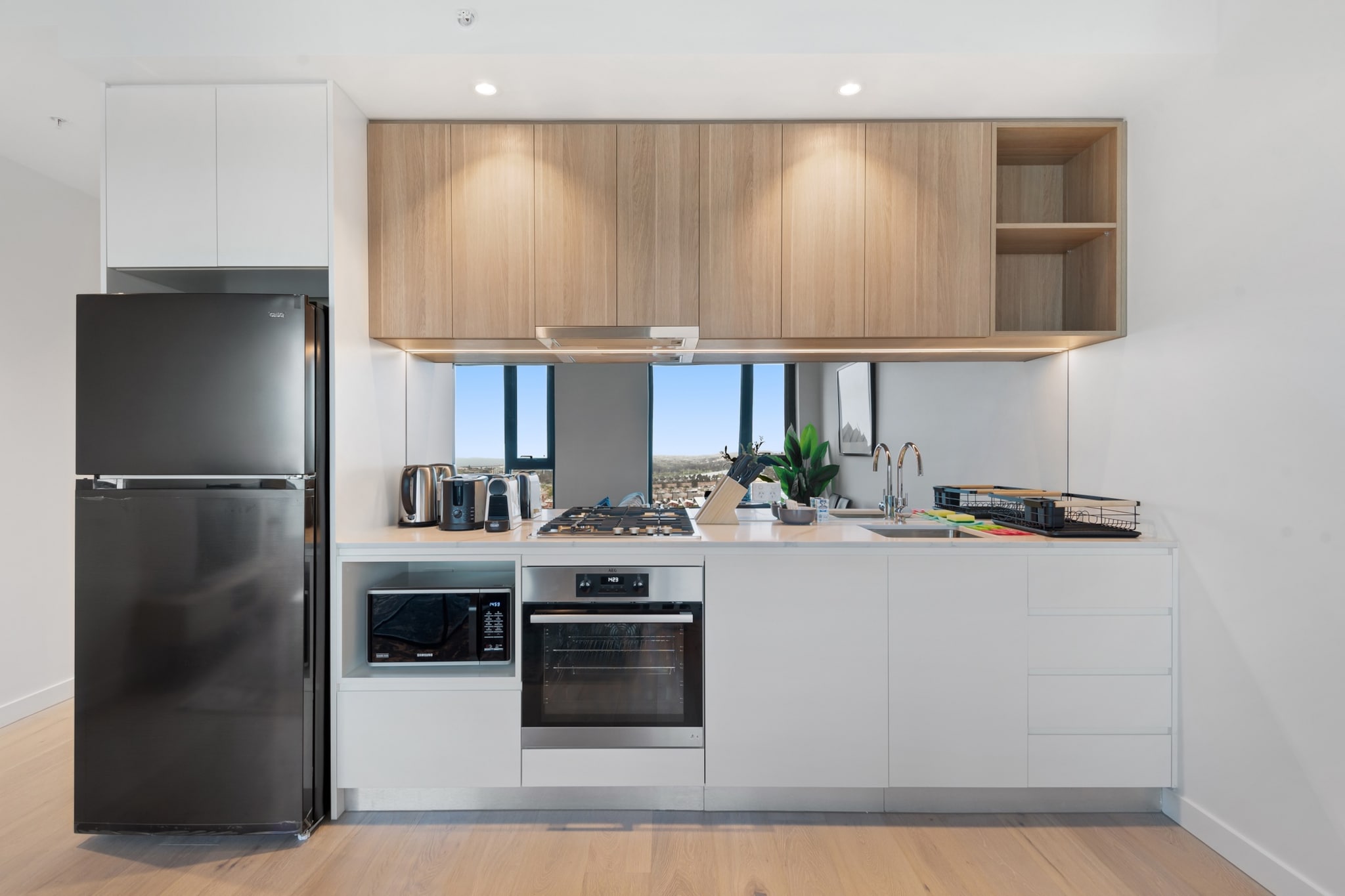 Located in the heart of trendy Southbank, indulge in this sophisticated 2-bed apartment boasting city and Bay views, bright interiors, minimalist decoration, and top-notch building facilities. Relax by the pool, exercise in the gym, host a dinner party in the private dining room, or simply go for a wander in the bustling streets of this inner-city suburb. Minutes away from shops, restaurants, the Crown Casino, and public transport, you cannot go wrong by staying in this gorgeous property.
The space
Meticulously designed with elegant minimalism, this chic inner-city unit features modern appliances, light timber floors, a open-plan living area, and a private balcony overlooking the city. The cosy queen bedrooms are soaked in light that comes through large windows, the bathroom is spacious and polished, and the kitchen has top-of-the-line appliances
 
Living room
- Couch sits 2 people
- TV with streaming options (use your own account- unavailable without Wi-Fi.)
 
Kitchen & Dining Area
- Fully equipped with cookware, utensils and cutlery
- Oven and gas stovetop
- Dining area sits 4 people
 
Bathroom & Laundry
- Laundry room available with washer
- Travel essentials, towels and hairdryer provided
 
Amenity Notes
- Large windows with bay views throughout
- A/C in living-area
- Wi-Fi is available
- Incredible building facilities: the pool, gym, rooftop terrace and lounge are on level 12, and private dining, BBQ space, and meeting rooms are on level 34. There are no restrictions on access, but private dining rooms are subject to booking.
- Whilst this property is located within a serviced building, it's managed external by us. Therefore, all the concierge services will not be applicable during your stay.
- No onsite parking
- Self check-in
Local area description
Southbank is known for its modern and upscale urban living, making it a popular choice for those who want to experience Melbourne's vibrant city life while enjoying the beauty of the Yarra River. The suburb is home to some of Melbourne's most iconic cultural institutions, including the National Gallery of Victoria (NGV) and the Arts Centre Melbourne. Southbank features a diverse array of restaurants, cafes, and bars. The suburb boasts several beautiful parks and green spaces along the river, including the Royal Botanic Gardens, Alexandra Gardens, and Birrarung Marr. These areas offer opportunities for picnicking, jogging, and enjoying outdoor activities. The region is well-connected to Melbourne's public transportation network, with tram services running along St Kilda Road and other major routes. The suburb is also within walking distance of Flinders Street Station, one of Melbourne's main transportation hubs.
House rules
You are staying in a friendly and peaceful neighbourhood and we kindly ask you to respect the community and your surrounding neighbours. The following strict House Rules apply:
 
- No loud noise between 10 pm and 8 am
- No parties or antisocial behaviour
- No additional people are to access the property without our prior approval
- No pets are allowed in the property without approval
- No smoking is allowed at any times
- If you break something, please let us know
- To help protect all floor coverings, do not wear any shoes inside the property
 
Please be aware that excessive noise such as amplified music, vocals or screaming or anti-social behaviour in the property or common areas can cause neighbours to complain to us, the Building Manager, Council Rangers or Police.
 
IMPORTANT:
- Any breach of the House Rules may lead to a $500 fine plus compensation for any cost/damage created and immediate eviction of the property without refund.
- Pets are available on request unless the property states it is pet friendly. Any stays with pets will incur an additional cleaning fee of $200.
 
Finally, when checking out, we kindly ask you for the following:
 
- Please leave all beds unmade
- Please clean up your dishes and put them away
- In case you have rearranged furniture, please put it back to the original location
- Please take out the rubbish and remember to use the right bins
- Please ensure all appliances, A/C and lights are off and doors and windows are closed.
- Please check your accommodation thoroughly before departing to avoid any unintentional items left behind.
 
We are not liable for any items left behind after your stay. In the rare event that a guest reports a missing item, we will make every effort to locate it for you, but we cannot guarantee its retrieval. If the item is found, we will gladly assist in arranging its return to an address within Australia, subject to postage and service fees.
Interaction with guests
Welcome to MadeComfy! Our local team curates stays in exceptional Australian & New Zealand properties, ensuring style, comfort, and prime locations for discerning guests. We prioritise your needs to provide a memorable home-away-from-home experience. Explore our digital guidebooks for local recommendations, and don't hesitate to contact us throughout your stay. We're here to ensure your comfort – enjoy your stay with MadeComfy.
Notes
For your comfort, this property is prepared with professional-grade hotel-style linen, including a three-sheet setup, ensuring a fresh and hygienic sleep experience.
 
Extra Services:
- Early check-in: Our standard check-in is at 3 pm. To guarantee early access to the property we suggest booking the night before if available. Otherwise, early check-in is subject to availability from the night before at an additional cost.
- Late check-out: Our standard check-out is at 10 am. To guarantee a later check-out of the property we suggest booking an additional night if available. Otherwise, a late check-out is subject to availability from the night before to an additional cost.
- Baggage: For security reasons, we are unable to receive or to keep unattended baggage before check-in or after check-out
- We provide a small welcome amenity pack to get your stay started
- This booking is protected with coverage for lost baggage and emergency medical expenses, provided by Travel Support with claim upto 500 AUD (T&C Applies). For more details reach out to Guest Support team post booking.
Access description
- The key collection is located offsite (300m from the property) and not available 24/7. Further details will be provided 3 days before check-in if your booking is successfully reserved. If check-in is outside of the opening hours and alternative check in method will be assigned.
- Stairs are required to access the outside of the property.
Getting around
Public transport
The closest tram stop is located 160 m away from the property on City Rd/Clarendon St. Please visit Transport Victoria's website for more information.
 
Getting There
The property is located 27 km away from Melbourne Airport.
By car, the journey will take around 25 minutes. By public transportation, the journey will take around 1 hour.
