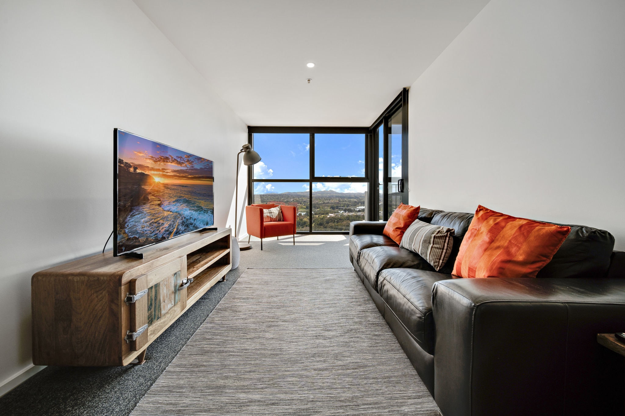 Near Canberra's CBD, this convenient lakeside 1-bed apartment presents spacious interiors, modern finishes, and heaps of natural light. Enjoy proximity to restaurants, bars, cafes, natural reserves, and easy city access with self-check-in. Guests of this apartment will enjoy the incredible building amenities, such as the indoor swimming pool. If you're visiting Canberra for work or leisure, this is an ideal base to enhance your trip.
The space
With outstanding views of Belconnen's green landscape and the scenic Lake Ginninderra, this modern abode includes a spotless kitchen and a comfortable living room with a designated reading nook overlooking the unmatched scenery. The queen-sized bedroom features built-in robes and is attached to an undercover balcony with seating facing the vista. This perfectly located unit has split A/C throughout, underground parking, internal laundry, and access facilities such as an indoor swimming pool. Close to shopping, transport, nature and hospitality venues, there cannot be a better place to upgrade your next Canberra holiday.
 
Living room
- Couch sits 3 people
- TV with free channels, Netflix and YouTube
 
Kitchen & Dining Area
- Fully equipped with cookware, utensils and cutlery
- Oven and induction stovetop
- Dining area sits 4 people
 
Bathroom & Laundry
- Laundry room available with washer and dryer
- Travel essentials, towels and hairdryer provided
 
Amenity Notes
- Comfortable bedroom with built-in robes & undercover balcony access overlooking the lake
- Split A/C throughout
- Wi-Fi is available
- Access to indoor pool, and other common-use facilities
- Secure underground parking for 1 vehicle
- Self check-in
Local area description
Belconnen is a suburb situated 7 km from Canberra's CBD. Serving as a prominent commercial and retail hub, it boasts Westfield Belconnen, one of Canberra's largest shopping centres and the esteemed University of Canberra. Belconnen offers ample recreational opportunities, notably around Lake Ginninderra, and is well-connected by a reliable public transport system, including a bus interchange. Its facilities encompass a library, community centres, and sports venues while hosting various cultural and sporting events, providing a dynamic living environment for its residents.
House rules
You are staying in a friendly and peaceful neighbourhood and we kindly ask you to respect the community and your surrounding neighbours. The following strict House Rules apply:
- No loud noise between 10 pm and 8 am
- No parties or antisocial behaviour
- No additional people are to access the property without our prior approval
- No pets are allowed in the property without approval
- No smoking is allowed at any times
- If you break something, please let us know
- To help protect all floor coverings, do not wear any shoes inside the property
 
Please be aware that excessive noise such as amplified music, vocals or screaming or anti-social behaviour in the property or common areas can cause neighbours to complain to us, the Building Manager, Council Rangers or Police.
 
IMPORTANT:
- Any breach of the House Rules may lead to a $500 fine plus compensation for any cost/damage created and immediate eviction of the property without refund.
- Pets are available on request unless the property states it is pet friendly. Any stays with pets will incur an additional cleaning fee of $200.
 
Finally, when checking out, we kindly ask you for the following:
- Please leave all beds unmade
- Please clean up your dishes and put them away
- In case you have rearranged furniture, please put it back to the original location
- Please take out the rubbish and remember to use the right bins
- Please ensure all appliances, A/C and lights are off and doors and windows are closed.
- Please check your accommodation thoroughly before departing to avoid any unintentional items left behind.
 
We are not liable for any items left behind after your stay. In the rare event that a guest reports a missing item, we will make every effort to locate it for you, but we cannot guarantee its retrieval. If the item is found, we will gladly assist in arranging its return to an address within Australia, subject to postage and service fees.
Interaction with guests
Welcome to MadeComfy! Our local team curates stays in exceptional Australian & New Zealand properties, ensuring style, comfort, and prime locations for discerning guests. We prioritise your needs to provide a memorable home-away-from-home experience. Explore our digital guidebooks for local recommendations, and don't hesitate to contact us throughout your stay. We're here to ensure your comfort – enjoy your stay with MadeComfy.
Notes
For your comfort, this property is prepared with professional-grade hotel-style linen, including a three-sheet setup, ensuring a fresh and hygienic sleep experience.
 
Extra Services:
- Early check-in: Our standard check-in is at 3 pm. To guarantee early access to the property we suggest booking the night before if available. Otherwise, early check-in is subject to availability from the night before at an additional cost.
- Late check-out: Our standard check-out is at 10 am. To guarantee a later check-out of the property we suggest booking an additional night if available. Otherwise, a late check-out is subject to availability from the night before to an additional cost.
- Baggage: For security reasons, we are unable to receive or to keep unattended baggage before check-in or after check-out
- We provide a small welcome amenity pack to get your stay started
- This booking is protected with coverage for lost baggage and emergency medical expenses, provided by Travel Support with claim upto 500 AUD (T&C Applies). For more details reach out to Guest Support team post booking.
Access description
- Key collection is 750 meters away from the property (3 min drive) due to no other check-in option available nearby the property. Check-in details will be provided 3 days before check-in if your booking is successfully reserved.
- Stairs are required to access the outside of the property.
Getting around
Public transport
Buses are the main form of public transport available near this property. The closest bus stop is located 21 m away from the property on Eastern Valley Way after Emu Bank Dr. Please visit Transport Canberra website for more information.
 
Getting There
The property is located 15 km away from Canberra Airport.
By car, the journey will take around 20 minutes. By public transportation, the journey will take around 1 hour and 15 minutes.