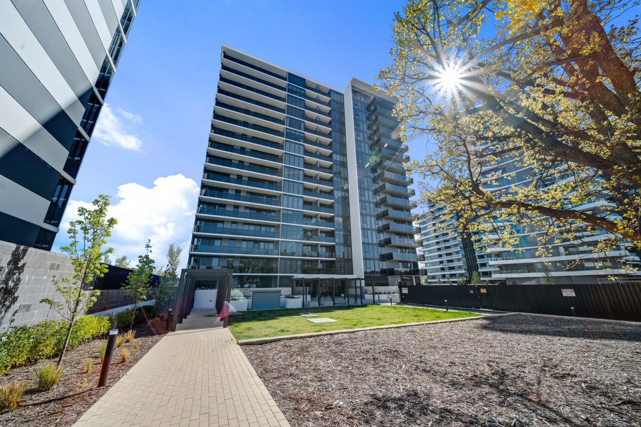 A quick 15-min drive to Canberra's CBD, this ultra sophisticated apartment presents chic interiors, modern finishes, an abundance of light and lots of space. The high-end interiors will guarantee your comfort whilst the building amenities will provide you entertainment, work spaces and relaxation. With self check-in and mere 2-min drive from the popular Woden Town Square and close to shopping, transport and hospitality venues, this property makes a convenient base for your next Canberra trip.

The space
Modern, bright and designed with meticulous attention to detail, this 1-bed apartment offers guests open-plan living sophistication. The spotless kitchen gives way to the elegant living room, where you can relax while enjoying the skyline views by the floor-to-ceiling windows. The immaculate bedroom features a queen-size bed, built-in robes and an out to the undercover balcony with seating overlooking the neighborhood.
 
Living room
- Couch sits 3 people
- TV with free channels and streaming options
 
Kitchen & Dining Area
- Fully equipped with cookware, utensils and cutlery
- Oven and gas stovetop
- Countertop sits 2, dining area sits 4 people
 
Bathroom & Laundry
- Laundry room available with washer and dryer
- Travel essentials, towels and hairdryer provided
 
Amenity Notes
- Split A/C throughout
- Wi-Fi is available
- Access to pool, gym, meeting spaces, and other entertainment areas
- Secure underground parking for 1 vehicle
Local area description
Known for its family-friendly atmosphere and convenient amenities, Phillip is located in the southern part of Canberra. The suburb offers attractions such as the Phillip Oval, a popular sports venue, and enjoys excellent public transport links through the nearby Woden Bus Interchange. Residents can also enjoy the bustling Westfield Woden shopping centre, offering diversity in shopping and entertainment options. With its proximity to Civic, the central business district, Phillip offers a well-rounded living experience for families, professionals, and retirees
House rules
You are staying in a friendly and peaceful neighbourhood and we kindly ask you to respect the community and your surrounding neighbours. The following strict House Rules apply:
- No loud noise between 10 pm and 8 am
- No parties or antisocial behaviour
- No additional people are to access the property without our prior approval
- No pets are allowed in the property without approval
- No smoking is allowed at any times
- If you break something, please let us know
- To help protect all floor coverings, do not wear any shoes inside the property
 
Please be aware that excessive noise such as amplified music, vocals or screaming or anti-social behaviour in the property or common areas can cause neighbours to complain to us, the Building Manager, Council Rangers or Police.
 
IMPORTANT:
- Any breach of the House Rules may lead to a $500 fine plus compensation for any cost/damage created and immediate eviction of the property without refund.
- Pets are available on request unless the property states it is pet friendly. Any stays with pets will incur an additional cleaning fee of $200.
 
Finally, when checking out, we kindly ask you for the following:
- Please leave all beds unmade
- Please clean up your dishes and put them away
- In case you have rearranged furniture, please put it back to the original location
- Please take out the rubbish and remember to use the right bins
- Please ensure all appliances, A/C and lights are off and doors and windows are closed.
- Please check your accommodation thoroughly before departing to avoid any unintentional items left behind.
 
We are not liable for any items left behind after your stay. In the rare event that a guest reports a missing item, we will make every effort to locate it for you, but we cannot guarantee its retrieval. If the item is found, we will gladly assist in arranging its return to an address within Australia, subject to postage and service fees.
Interaction with guests
Welcome to MadeComfy! Our local team curates stays in exceptional Australian & New Zealand properties, ensuring style, comfort, and prime locations for discerning guests. We prioritise your needs to provide a memorable home-away-from-home experience. Explore our digital guidebooks for local recommendations, and don't hesitate to contact us throughout your stay. We're here to ensure your comfort – enjoy your stay with MadeComfy.
Notes
- For your comfort, this property is prepared with professional-grade hotel-style linen, including a three-sheet setup, ensuring a fresh and hygienic sleep experience.
- No pets are allowed to stay in the property
 
Extra Services:
- Early check-in: Our standard check-in is at 3 pm. To guarantee early access to the property we suggest booking the night before if available. Otherwise, early check-in is subject to availability from the night before at an additional cost.
- Late check-out: Our standard check-out is at 10 am. To guarantee a later check-out of the property we suggest booking an additional night if available. Otherwise, a late check-out is subject to availability from the night before to an additional cost.
- Baggage: For security reasons, we are unable to receive or to keep unattended baggage before check-in or after check-out
- We provide a small welcome amenity pack to get your stay started
- This booking is protected with coverage for lost baggage and emergency medical expenses, provided by Travel Support with claim upto 500 AUD (T&C Applies). For more details reach out to Guest Support team post booking.
Access description
- The key collection is located onsite. Further details will be provided 3 days before check-in if your booking is successfully reserved.
Getting around
Public transport
Buses are the main form of public transport available near this property. The closest bus stop is located 400m away from the property on Launceston St before Furzer St. Please visit Transport Canberra website for more information.
 
Getting There
The property is located 15 km away from Canberra Airport.
By car, the journey will take around 17 minutes. By public transportation, the journey will take around 1 hour and 30 minutes.