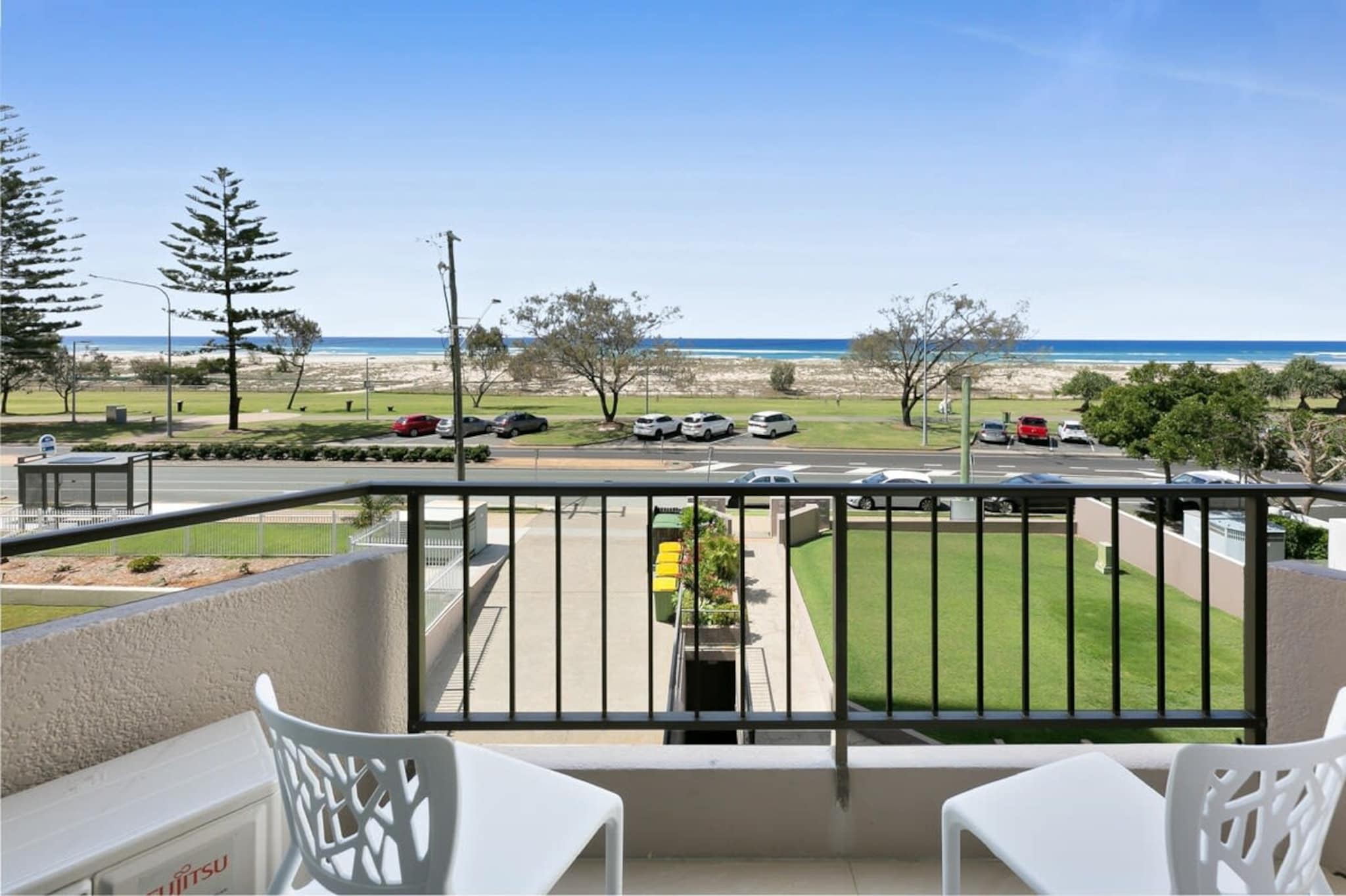 There is no better place to relax in the sun than the sunny Gold Coast. Immerse yourself in the laid-back atmosphere of trendy Coolangatta in this pristine studio apartment framed by large windows and a cosy balcony overlooking the picturesque Kirra Beach — which is just across the road. Within walking distance to boutique cafes, shops, restaurants, the beach, and public transport, with the added convenience of self-check-in, this property is the perfect destination for your next holiday.
The space
Located 250 metres from the patrolled surfing paradise Kirra Beach and a mere 4-minute drive to swimming, fishing and diving sanctuary Coolangatta Beach, this modern studio ticks all the boxes for a perfect holiday home. With an easy open-plan setup, the apartment showcases lots of natural light pouring through the large windows. The undercover balcony overlooks the golden sands and crystal waves of Kirra Beach. The bedroom is comfortable and features a queen-sized bed, and built-in robes with plenty of storage. If you like cooking, your experience will be enhanced by the view of the ocean as the backdrop.This lovely home also features a polished bathroom with walk-in shower and internal laundry facility, split system A/C to help you cool off or warm up, and the convenience of self check-in. Within walking distance to everything you'll need, this beach abode has your name written all over it.
 
Living room
- Couch sits 2 people
- TV with free air channels, Pay TV, Cable TV, Foxtel, and Netflix available
 
Kitchen & Dining Area
- Fully equipped with cookware, utensils and cutlery
- Oven and electric stovetop
- Countertop area sits 2 people
 
Bathroom & Laundry
- Washer and dryer provided
- Clothes lines are located at the rear of the apartment building
- Travel essentials, towels and hairdryer provided
 
Amenity Notes
- Split system A/C (heating + cooling)
- Two ceiling fans (living area + bedroom)
- Wi-Fi is available
- Private undercover balcony overlooking Kirra Beach
- One parking spot is available, suitable for small to medium-sized cars and SUVs only.
Local area description
Coolangatta is a charming suburb located in Queensland, renowned for its picturesque beaches and vibrant atmosphere. Situated on the Gold Coast, it boasts stunning coastlines ideal for surfing, swimming, and relaxing in the sun. The suburb is dotted with trendy cafes, boutique shops, and a lively esplanade that offers stunning views of the Pacific Ocean. With its laid-back lifestyle and a mix of recreational activities, Coolangatta attracts locals and tourists seeking a perfect blend of beachside tranquillity and urban conveniences.
House rules
You are staying in a friendly and peaceful neighbourhood and we kindly ask you to respect the community and your surrounding neighbours. The following strict House Rules apply:
- No loud noise between 10 pm and 8 am
- No parties or antisocial behaviour
- No additional people are to access the property without our prior approval
- No pets are allowed in the property without approval
- No smoking is allowed at any times
- If you break something, please let us know
- To help protect all floor coverings, do not wear any shoes inside the property
 
Please be aware that excessive noise such as amplified music, vocals or screaming or anti-social behaviour in the property or common areas can cause neighbours to complain to us, the Building Manager, Council Rangers or Police.
 
IMPORTANT:
- Any breach of the House Rules may lead to a $500 fine plus compensation for any cost/damage created and immediate eviction of the property without refund.
- Pets are available on request unless the property states it is pet friendly. Any stays with pets will incur an additional cleaning fee of $200.
 
Finally, when checking out, we kindly ask you for the following:
- Please leave all beds unmade
- Please clean up your dishes and put them away
- In case you have rearranged furniture, please put it back to the original location
- Please take out the rubbish and remember to use the right bins
- Please ensure all appliances, A/C and lights are off and doors and windows are closed.
- Please check your accommodation thoroughly before departing to avoid any unintentional items left behind.
 
We are not liable for any items left behind after your stay. In the rare event that a guest reports a missing item, we will make every effort to locate it for you, but we cannot guarantee its retrieval. If the item is found, we will gladly assist in arranging its return to an address within Australia, subject to postage and service fees.
Interaction with guests
Welcome to MadeComfy! Our local team curates stays in exceptional Australian & New Zealand properties, ensuring style, comfort, and prime locations for discerning guests. We prioritise your needs to provide a memorable home-away-from-home experience. Explore our digital guidebooks for local recommendations, and don't hesitate to contact us throughout your stay. We're here to ensure your comfort – enjoy your stay with MadeComfy.
Notes
For your comfort, this property is prepared with professional-grade hotel-style linen, including a three-sheet setup, ensuring a fresh and hygienic sleep experience.
 
Extra Services:
- Early Check-in: Our standard check-in is at 3 pm. To guarantee early access to the property we suggest booking the night before if available. Otherwise, early check-in is subject to availability from the night before at an additional cost.
- Late check-out: Our standard check-out is at 10 am. To guarantee a later check-out of the property we suggest booking an additional night if available. Otherwise, a late check-out is subject to availability from the night before to an additional cost.
- Baggage: For security reasons, we are unable to receive or to keep unattended baggage before check-in or after check-out
- We provide a small welcome amenity pack to get your stay started
- This booking is protected with coverage for lost baggage and emergency medical expenses, provided by Travel Support with claim upto 500 AUD (T&C Applies). For more details reach out to Guest Support team post booking.
Access description
- The keys will be left in a lockbox onsite. We will send you the access code 3 days prior to your arrival through the booking portal.
- Stairs are required to access the building and the unit.
Getting around
Public transport
The closest bus stop is located 140 m away from the property on Musgrave St at Kirra shops. Please visit Translink's website for more information.
 
Getting There
The property is located 1.2 km away from Gold Coast Airport.
By car, the journey will take around 2 minutes. By public transportation, the journey will take around 14 minutes.