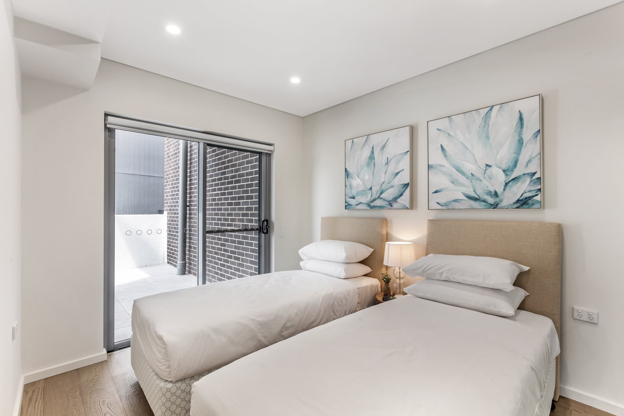 Indulge in Kiama's serene ambiance within this exquisite brand-new ground floor unit boasting generous interiors and close proximity to parks, conveniences, transportation, and several breathtaking beaches along the South Coast of NSW. Equipped with central air conditioning, onsite parking, and seamless access to Kiama's prime destinations, this residence is ready to help you create memories with loved ones amidst this coastal paradise.
The space
This pristine property embodies sophistication and tranquillity with its fresh, refined design and expansive interiors crafted for unwinding. Boasting an effortless open-plan layout with dining and living spaces, this home showcases luminous timber flooring, a discreet yet modern kitchen furnished with state-of-the-art appliances, 3 exquisite bedrooms with built-in wardrobes and expansive windows, 2 chic bathrooms featuring walk-in showers, and a secluded covered balcony offering an alfresco dining experience by the building's serene gardens. Positioned within close proximity of local restaurants and shops, and just moments away by car from idyllic destinations like Loves Bay, Eats Beach, Little Blowhole, Kendalls Beach, and the renowned Kiama Surf Beach, this abode is the place to be for the best of NSW coastal living.
 
Living room
- Couch sits 4 people & 2 additional armchairs
- TV with free air channels and streaming apps (guest to use own credentials)
 
Kitchen & Dining Area
- Equipped with utensils and cutlery
- Oven and gas stovetop
- Dining area sits 6 people
 
Bathroom & Laundry
- Laundry room available with washer and dryer
- Travel essentials, towels and hairdryer provided
 
Amenity Notes
- Ducted A/C (heating + cooling) throughout
- Wi-Fi is provided
- Ground Floor unit
- Study Nook
- Garage parking for 2 vehicles
- BBQ is available
- Amenity access: private undercover balcony with alfresco dining
Local area description
Kiama is a picturesque coastal town in the Illawarra region of New South Wales. Known for its stunning landscapes, it's famous for the Kiama Blowhole — a natural rock formation where seawater shoots up into the air, creating an impressive display. The town offers lush greenery, beautiful beaches like Surf Beach and Jones Beach, and coastal walks with breathtaking views of the Pacific Ocean. Kiama exudes a relaxed atmosphere, with a charming town centre featuring cafes, boutique shops, and a friendly community vibe. With its blend of natural beauty and coastal charm, Kiama is a sought-after destination for tourists and locals seeking a tranquil seaside retreat.
House rules
You are staying in a friendly and peaceful neighbourhood and we kindly ask you to respect the community and your surrounding neighbours. The following strict House Rules apply:
 
- No loud noise between 10 pm and 8 am
- No parties or antisocial behaviour
- No additional people are to access the property without our prior approval
- No smoking is allowed at any times
- If you break something, please let us know
- Pets are allowed upon request, Please note that an additional cleaning fee of AUD 200 will apply for stays with pets.
- No skateboards or scooters allowed within the building premises including parking lot
- To help protect all floor coverings, do not wear any shoes inside the property
 
Please be aware that excessive noise such as amplified music, vocals or screaming or anti-social behaviour in the property or common areas can cause neighbours to complain to us, the Building Manager, Council Rangers or Police.
 
IMPORTANT:
 
- Any breach of the House Rules may lead to a $500 fine plus compensation for any cost/damage created and immediate eviction of the property without refund.
 
Finally, when checking out, we kindly ask you for the following:
- Please leave all beds unmade
- Please clean up your dishes and put them away
- In case you have rearranged furniture, please put it back to the original location
- Please take out the rubbish and remember to use the right bins
- Please ensure all appliances, A/C and lights are off and doors and windows are closed.
- Please check your accommodation thoroughly before departing to avoid any unintentional items left behind.
 
We are not liable for any items left behind after your stay. In the rare event that a guest reports a missing item, we will make every effort to locate it for you, but we cannot guarantee its retrieval. If the item is found, we will gladly assist in arranging its return to an address within Australia, subject to postage and service fees.
 
Important Notice: Garage Security Alert
 
To ensure everyone's safety, we kindly ask you to follow these precautions during your stay:
 
- Be Vigilant: If you see anyone in the garage whom you do not recognise, remain aware of your surroundings and proceed with caution.
- Access Control: Do not allow unknown vehicles to follow you into the garage. If another car approaches while you are entering, ensure they have the appropriate access before proceeding.
- Walking Through the Garage: Remain observant when walking through the garage, especially if you notice unfamiliar individuals.
- Security Cameras: Our cameras are being upgraded, but not all areas are covered at this time. Please stay alert and take precautions.
- Reporting Issues: If you notice anything suspicious or if something is missing, please file a police report and inform Building Management immediately.
 
We appreciate your cooperation in helping maintain a safe and secure environment for everyone. Thank you for your understanding.
Interaction with guests
Welcome to MadeComfy! Our local team curates stays in exceptional Australian & New Zealand properties, ensuring style, comfort, and prime locations for discerning guests. We prioritise your needs to provide a memorable home-away-from-home experience. Explore our digital guidebooks for local recommendations, and don't hesitate to contact us throughout your stay. We're here to ensure your comfort – enjoy your stay with MadeComfy.
Notes
- For your comfort, this property is prepared with professional-grade hotel-style linen, including a three-sheet setup, ensuring a fresh and hygienic sleep experience.
- E-bikes shouldn't be charged overnight or left on without supervision.
- Please note that the property is located next to a train line some noise may be noticeable during your stay.
 
Pet Rules:
- We only welcome small to medium-sized pets upon request, additional fees apply.
- Guests are required to contact the host and provide a picture of their pet prior to arrival.
 
Extra Services:
- Early Check-in: Our standard check-in is at 3 pm. To guarantee early access to the property we suggest booking the night before if available. Otherwise, early check-in is subject to availability from the night before at an additional cost.
- Late check-out: Our standard check-out is at 10 am. To guarantee a later check-out of the property we suggest booking an additional night if available. Otherwise, a late check-out is subject to availability from the night before to an additional cost.
- Baggage: For security reasons, we are unable to receive or to keep unattended baggage before check-in or after check-out
- We provide a small welcome amenity pack to get your stay started
 
Important Notice: Garage Security Alert
 
To ensure everyone's safety, we kindly ask you to follow these precautions during your stay:
 
- Be Vigilant: If you see anyone in the garage whom you do not recognise, remain aware of your surroundings and proceed with caution.
- Access Control: Do not allow unknown vehicles to follow you into the garage. If another car approaches while you are entering, ensure they have the appropriate access before proceeding.
- Walking Through the Garage: Remain observant when walking through the garage, especially if you notice unfamiliar individuals.
- Security Cameras: Our cameras are being upgraded, but not all areas are covered at this time. Please stay alert and take precautions.
- Reporting Issues: If you notice anything suspicious or if something is missing, please file a police report and inform Building Management immediately.
 
We appreciate your cooperation in helping maintain a safe and secure environment for everyone. Thank you for your understanding.
- This booking is protected with coverage for lost baggage and emergency medical expenses, provided by Travel Support with claim upto 500 AUD (T&C Applies). For more details reach out to Guest Support team post booking.
Access description
- Self-check in will happen on site. Further details will be provided 3 days before check-in if your booking is successfully reserved.
Getting around
Public transport
The closest bus stop is located 1 km from the property on Hillview Cct after Stewart Pl. Please visit Transport NSW website for more information.
 
Getting There
The property is located 20 km away from Shellharbour Airport.
By car, the journey will take around 20 minutes. By public transportation, the journey will take around 1 hour and 20 minutes.