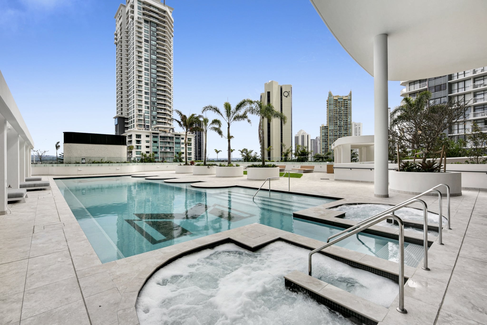 Overlooking the famous Surfers Paradise Beach from the 37th floor, this incredible 1-bedroom apartment offers beautiful, naturally light-filled interiors. A stone's throw from the beach, this airy, open-plan pad features floor-to-ceiling windows and a large sunroom with sweeping ocean views. With outstanding building amenities – including indoor/outdoor pools, a spa, sauna, and more – you'll have easy access to shops, restaurants, and nature-centric attractions along the beachfront or the serene
The space
Luxury, sophistication, and unmatched views – that's what you'll experience in this exquisite Surfers Paradise apartment. With sweeping ocean views from nearly every room, this chic home features self-check-in, an open-plan layout, a contemporary kitchen, and a comfortable living area. The generous sunroom with breathtaking ocean views is the perfect place to observe the suburb's natural beauty from up high. Meticulously designed, the bedroom also overlooks the ocean, while the bathroom is polished and ideal for recharging after a day in the sun. Guests of this property have exclusive access to a plethora of amenities, including an indoor sky pool, spa, sauna, outdoor pool, onsite restaurants, and a beachside cafe. With Surfers Paradise's exciting attractions at your doorstep, this property promises an unforgettable summer holiday.
 
Living room
- Couch sits 4 people
- TV with YouTube and Netflix available
 
Kitchen & Dining Area
- Equipped with utensils and cutlery
- Oven and gas stovetop
- Dining area sits 4 people
 
Bathroom & Laundry
- Laundry room available with washer and dryer
- Travel essentials, towels and hairdryer provided
 
Amenity Notes
- Ducted A/C (heating + cooling) throughout
- Wi-Fi is provided
- Amenities operational hours: 5:00 am - 10 pm.
Local area description
Surfers Paradise is a dynamic and bustling destination that attracts tourists from all over the world. Its combination of stunning natural beauty, modern amenities, and lively atmosphere makes it a popular choice for vacationers seeking sun, sea, and a vibrant social scene. It's known for its stunning sandy beaches, vibrant nightlife, and high-rise skyline — the Q1 building, which was once the tallest residential tower in the world, is one of the most prominent landmarks. The area is home to various shopping precincts and dining options. You'll find everything from boutique shops to large shopping centres like Chevron Renaissance and Circle on Cavill. There are also numerous restaurants, cafes, and bars offering a wide range of cuisines. Surfers Paradise is renowned for its lively nightlife which includes nightclubs, bars, and live music venues. The suburb has a light rail system, known as the G:link, which provides easy access to neighbouring suburbs and attractions.
House rules
You are staying in a friendly and peaceful neighbourhood and we kindly ask you to respect the community and your surrounding neighbours. The following strict House Rules apply:
- No loud noise between 10 pm and 8 am
- No parties or antisocial behaviour
- No additional people are to access the property without our prior approval
- No pets are allowed in the property without approval
- No smoking is allowed at any times
- If you break something, please let us know
- To help protect all floor coverings, do not wear any shoes inside the property
 
Please be aware that excessive noise such as amplified music, vocals or screaming or anti-social behaviour in the property or common areas can cause neighbours to complain to us, the Building Manager, Council Rangers or Police.
 
IMPORTANT:
- Any breach of the House Rules may lead to a $500 fine plus compensation for any cost/damage created and immediate eviction of the property without refund.
- Pets are available on request unless the property states it is pet friendly. Any stays with pets will incur an additional cleaning fee of $200.
 
Finally, when checking out, we kindly ask you for the following:
- Please leave all beds unmade
- Please clean up your dishes and put them away
- In case you have rearranged furniture, please put it back to the original location
- Please take out the rubbish and remember to use the right bins
- Please ensure all appliances, A/C and lights are off and doors and windows are closed.
- Please check your accommodation thoroughly before departing to avoid any unintentional items left behind.
 
We are not liable for any items left behind after your stay. In the rare event that a guest reports a missing item, we will make every effort to locate it for you, but we cannot guarantee its retrieval. If the item is found, we will gladly assist in arranging its return to an address within Australia, subject to postage and service fees.
Interaction with guests
Welcome to MadeComfy! Our local team curates stays in exceptional Australian & New Zealand properties, ensuring style, comfort, and prime locations for discerning guests. We prioritise your needs to provide a memorable home-away-from-home experience. Explore our digital guidebooks for local recommendations, and don't hesitate to contact us throughout your stay. We're here to ensure your comfort – enjoy your stay with MadeComfy.
Notes
For your comfort, this property is prepared with professional-grade hotel-style linen, including a three-sheet setup, ensuring a fresh and hygienic sleep experience.
 
Extra Services:
- Early Check-in: Our standard check-in is at 3 pm. To guarantee early access to the property we suggest booking the night before if available. Otherwise, early check-in is subject to availability from the night before at an additional cost.
- Late check-out: Our standard check-out is at 10 am. To guarantee a later check-out of the property we suggest booking an additional night if available. Otherwise, a late check-out is subject to availability from the night before to an additional cost.
- Baggage: For security reasons, we are unable to receive or to keep unattended baggage before check-in or after check-out
- We provide a small welcome amenity pack to get your stay started.
- This booking is protected with coverage for lost baggage and emergency medical expenses, provided by Travel Support with claim upto 500 AUD (T&C Applies). For more details reach out to Guest Support team post booking.
Access description
The key collection is located offsite (900m from the property) and not available 24/7. Further details will be provided 3 days before check-in if your booking is successfully reserved. If check-in is outside of the opening hours and alternative check in method will be assigned.
Getting around
Public transport
The closest light rail stop is located 200 m from the property on Cypress Avenue. The closest bus stop is located 400 m from the property on Ferny Ave at Palm Avenue. Please visit Translink's website for more information.
 
Getting There
The property is located 22 km away from Gold Coast Airport.
By car, the journey will take around 45 minutes. By public transportation, the journey will take around 55 minutes.