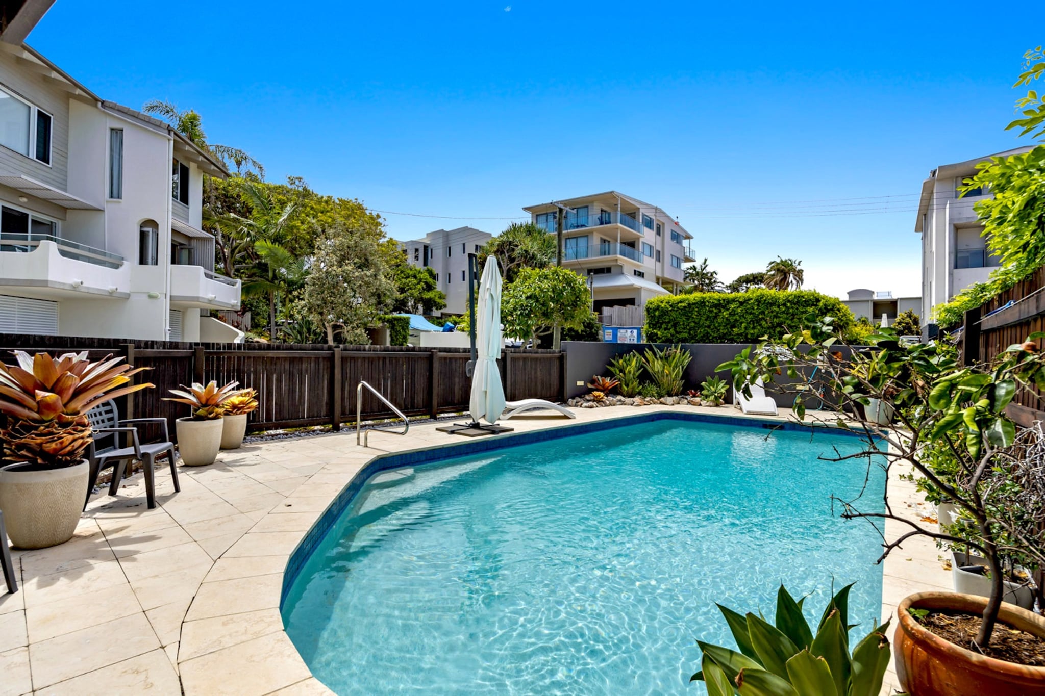 This incredible 2-bed townhouse is located within walking distance from one of Queensland's stunning hidden gems: Sunshine Beach. Featuring bright and comfortable interiors, find yourself within minutes from the beach, parks, and a selection of restaurants, cafes, and shops in the famous neighbouring suburb Noosa. With parking on-site for 1 car and A/C, this property promises to be an ideal base for a beach holiday with family or friends.
The space
Situated in the heart of Sunshine Beach – a location known for its sunshine, good surf and white sands – this 2-bed, 1-bath property is spacious, sunny and tastefully decorated. The roomy open-plan living area features a fully-equipped kitchen and a snug living room overlooking the lovely undercover balcony with sparkling ocean views. With bright bedrooms, a spacious bathroom, a private patio with BBQ area, and access to a refreshing swimming pool, this residence won't disappoint you. Within walking distance to Sunshine Beach and only a stone's throw to famous Noosa Beach, experience the convenience of being in close proximity to shops, restaurants, and public transport whilst relaxing in this impeccable home featuring split air conditioning and secure parking.
 
Living room
- Seating in the lounge area for 5 people
- TV with free air channels and Netflix (guest's credentials required) available
 
Kitchen & Dining Area
- Fully equipped with utensils and cutlery
- Oven and induction stovetop
- Countertop area sits 2 people and dining area sits 4 people
 
Bathroom & Laundry
- Laundry room available with washer and dryer
- Travel essentials, towels and hairdryer provided
 
Amenity Notes
- Split A/C (heating + cooling)
- Wi-Fi is provided
- Garage parking for 1 small to medium vehicle
- Self check-in
- Amenity access: private balcony with seating overlooking greenery and the ocean, private patio with BBQ and alfresco dining, swimming pool
- Outdoor pool is not heated
- Top floor loft ideal for reading and relaxing. Stairs are steep to access, not suitable for children