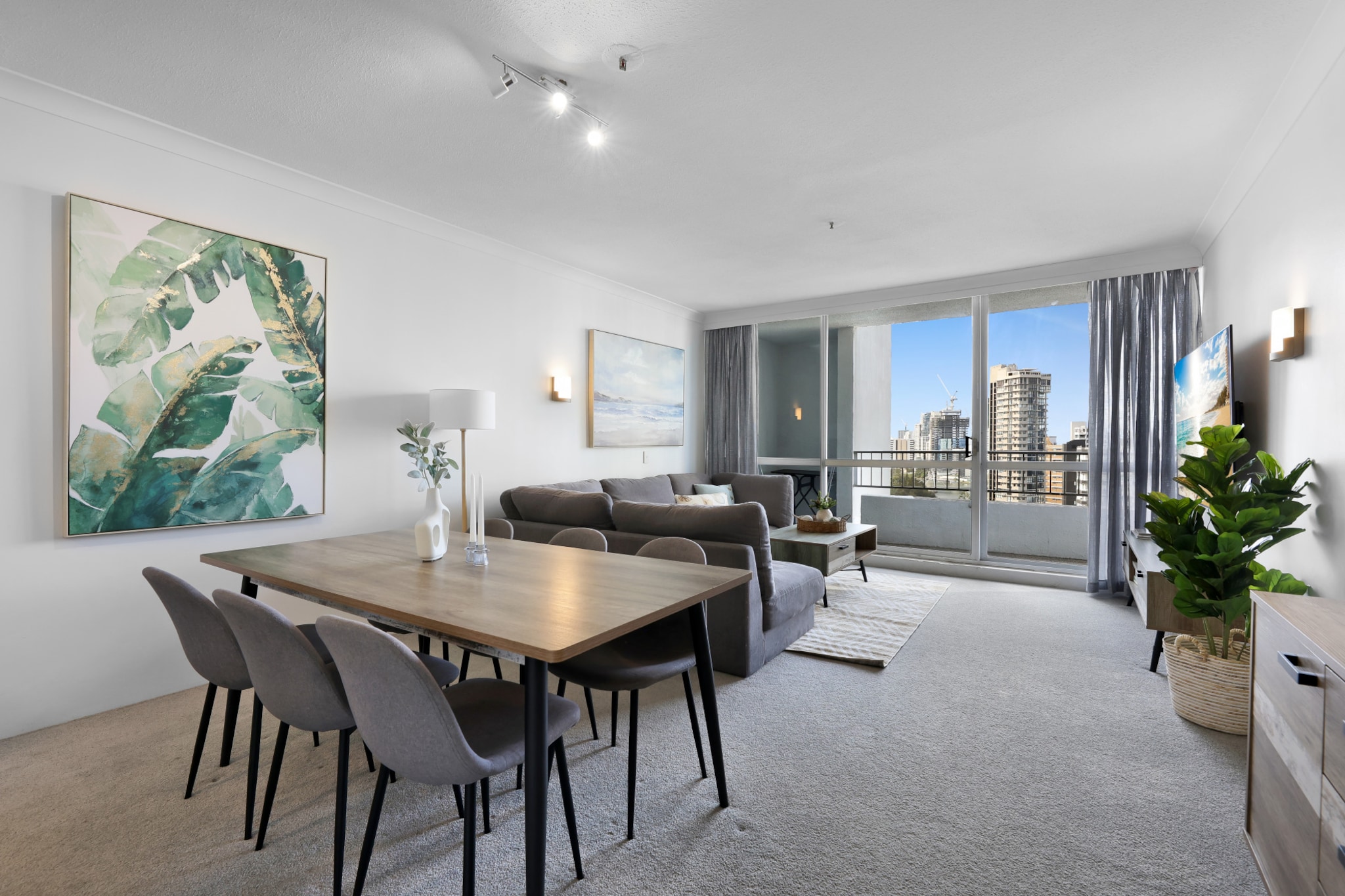 Elevated on a high floor, this stylish 2-bedroom apartment located in the Golden Gate Building, boasts a mesmerising view of Surfers Paradise skyline and ocean, with interiors bathed in natural light. A brief stroll from the beach, this open-plan residence features floor-to-ceiling windows and outstanding amenities, including a swimming pool, playground, BBQ area, and more. Perfect for a family getaway, this is the ultimate destination to experience the best of coastal living.
The space
Find refinement and comfort with unmatched skyline and ocean views in this Surfers Paradise apartment. This sophisticated apartment features an open-plan layout, a contemporary kitchen, and a cosy living area. Meticulously designed, the chic bedrooms are elegant and bright. The apartment offers the perfect retreat after a day of fun, and is a prime location for the GC500. Guests at this property relish exclusive access to outstanding amenities, including a swimming pool, playground, tennis court, basketball hoop, and BBQ area. With the vibrant attractions, restaurants, and cafes of Surfers Paradise mere steps away, this property ensures an unforgettable summer holiday experience.
 
Living room
- Couch sits 4 people
- Smart TV with free air channels, and streaming apps available
 
Kitchen & Dining Area
- Fully equipped with utensils and cutlery
- Oven and type stovetop
- Dining area sits 6 people
 
Bathroom & Laundry
- Laundry room available with washer and dryer
- Travel essentials, towels and hairdryer provided
 
Amenity Notes
- Ducted A/C (heating + cooling) throughout
- Wi-Fi available
- Free secure parking for 1 medium-sized vehicle height restriction is 2 metres
- Amenity access: private balcony overlooking the ocean; communal swimming pool, playground, tennis court, basketball hoop, communal BBQ area
- Surfers Paradise's famous Esplanade is 250 meters away
- 270m from a patrolled beach
Local area description
Surfers Paradise is a dynamic and bustling destination that attracts tourists from all over the world. Its combination of stunning natural beauty, modern amenities, and lively atmosphere makes it a popular choice for vacationers seeking sun, sea, and a vibrant social scene. It's known for its stunning sandy beaches, vibrant nightlife, and high-rise skyline — the Q1 building, which was once the tallest residential tower in the world, is one of the most prominent landmarks. The area is home to various shopping precincts and dining options. You'll find everything from boutique shops to large shopping centres like Chevron Renaissance and Circle on Cavill. There are also numerous restaurants, cafes, and bars offering a wide range of cuisines. Surfers Paradise is renowned for its lively nightlife which includes nightclubs, bars, and live music venues. The suburb has a light rail system, known as the G:link, which provides easy access to neighbouring suburbs and attractions.
House rules
You are staying in a friendly and peaceful neighbourhood and we kindly ask you to respect the community and your surrounding neighbours. The following strict House Rules apply:
 
- No loud noise between 10 pm and 8 am
- No parties or antisocial behaviour
- No additional people are to access the property without our prior approval
- No pets are allowed in the property without approval
- No smoking is allowed at any times
- If you break something, please let us know
- To help protect all floor coverings, do not wear any shoes inside the property
 
Please be aware that excessive noise such as amplified music, vocals or screaming or anti-social behaviour in the property or common areas can cause neighbours to complain to us, the Building Manager, Council Rangers or Police.
 
IMPORTANT:
- Any breach of the House Rules may lead to a $500 fine plus compensation for any cost/damage created and immediate eviction of the property without refund.
- Pets are available on request unless the property states it is pet friendly. Any stays with pets will incur an additional cleaning fee of $200.
 
Finally, when checking out, we kindly ask you for the following:
 
- Please leave all beds unmade
- Please clean up your dishes and put them away
- In case you have rearranged furniture, please put it back to the original location
- Please take out the rubbish and remember to use the right bins
- Please ensure all appliances, A/C and lights are off and doors and windows are closed.
- Please check your accommodation thoroughly before departing to avoid any unintentional items left behind.
 
We are not liable for any items left behind after your stay. In the rare event that a guest reports a missing item, we will make every effort to locate it for you, but we cannot guarantee its retrieval. If the item is found, we will gladly assist in arranging its return to an address within Australia, subject to postage and service fees.
Interaction with guests
Welcome to MadeComfy! Our local team curates stays in exceptional Australian & New Zealand properties, ensuring style, comfort, and prime locations for discerning guests. We prioritise your needs to provide a memorable home-away-from-home experience. Explore our digital guidebooks for local recommendations, and don't hesitate to contact us throughout your stay. We're here to ensure your comfort – enjoy your stay with MadeComfy.
Notes
For your comfort, this property is prepared with professional-grade hotel-style linen, including a three-sheet setup, ensuring a fresh and hygienic sleep experience.
 
Extra Services:
- Early Check-in: Our standard check-in is at 3 pm. To guarantee early access to the property we suggest booking the night before if available. Otherwise, early check-in is subject to availability from the night before at an additional cost.
- Late check-out: Our standard check-out is at 10 am. To guarantee a later check-out of the property we suggest booking an additional night if available. Otherwise, a late check-out is subject to availability from the night before to an additional cost.
- Baggage: For security reasons, we are unable to receive or to keep unattended baggage before check-in or after check-out
- We provide a small welcome amenity pack to get your stay started.
- This booking is protected with coverage for lost baggage and emergency medical expenses, provided by Travel Support with claim upto 500 AUD (T&C Applies). For more details reach out to Guest Support team post booking.
Access description
- Keys are located 1.3 km away from the property, full check-in details will be provided 3 days before check-in if your booking is successfully reserved.
Getting around
Public transport:
Surfers Paradise North Tram stop is 120m away from the property. The closest bus stop is located 100 m from the property on Surfers Paradise North station. Please visit Translink's website for more information.
 
Chevron Renaissance Shopping Centre 950m away.
 
Getting There
The property is located 31 km away from Gold Coast Airport.
By car, the journey will take around 40 minutes. By public transportation, the journey will take around 50 minutes.