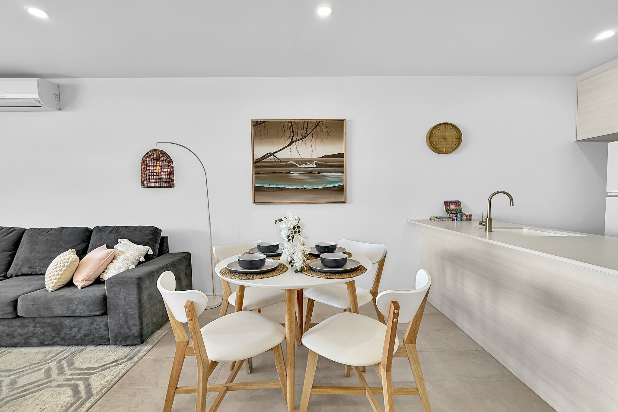 Step into the seaside allure of Batemans Bay with this expansive 1-bed apartment with breathtaking ocean views. Just moments away from the area's main attractions, this light-filled abode offers a perfect blend of tranquillity and accessibility. Enjoy the spacious interiors, alfresco dining on the balcony, and refreshing dips in the rooftop swimming pool. With A/C, on-site parking and stunning beaches around, Batemans Bay beckons as the ultimate getaway destination for coastal bliss.
The space
Wake up to the allure of Batemans Bay, where stunning beaches, national parks, and scenic river walks await your exploration. This comfortable 1-bedroom apartment offers a perfect retreat in the heart of this picturesque suburb. Enjoy its spacious and bright interiors, fully-equipped kitchen, spa-like bathroom, and inviting lounge and dining areas. Outside, unwind in the private sea-facing balcony with outdoor dining setup or take a dip in the refreshing rooftop swimming pool. With modern comforts like air conditioning and underground parking, along with the convenience of self check-in, this seaside oasis promises an unforgettable getaway. Treat yourself to a slice of paradise tailored for unforgettable memories.
 
Living room
- Couch sits 4 people
- TV with free air channels and streaming apps available (guests to use with their own accounts)
 
Kitchen & Dining Area
- Fully equipped with utensils and cutlery
- Oven and induction stovetop
- Dining area sits 4 people
 
Bathroom & Laundry
- Laundry room available with washer and dryer
- Travel essentials, towels and hairdryer provided
 
Amenity Notes
- Split A/C (heating + cooling) throughout
- Wi-Fi available
- Underground parking for 1 medium-sized vehicle
- Amenity access: private balcony with alfresco dining overlooking the ocean and building rooftop swimming pool.
Local area description
Batemans Bay, nestled on the stunning south coast of New South Wales, embodies a harmonious blend of coastal charm and natural beauty. As the region's commercial hub, it offers a picturesque waterfront embraced by pristine beaches, including the popular Surfside and Catalina. The Clyde River, weaving through the town, provides a serene backdrop for leisurely activities such as fishing, boating, and kayaking. Its vibrant community celebrates diverse events, from local markets showcasing regional produce to cultural festivals. With its proximity to Murramarang National Park and Eurobodalla National Park, Batemans Bay beckons nature enthusiasts with opportunities for bushwalks, wildlife spotting, and breathtaking scenic lookouts. The town's relaxed ambience, coastal allure, and abundant outdoor pursuits, makes it a captivating destination for residents and tourists.
House rules
You are staying in a friendly and peaceful neighbourhood and we kindly ask you to respect the community and your surrounding neighbours. The following strict House Rules apply:
 
- No loud noise between 10 pm and 8 am
- No parties or antisocial behaviour
- No additional people are to access the property without our prior approval
- No pets are allowed in the property
- No smoking is allowed at any times
- If you break something, please let us know
- To help protect all floor coverings, do not wear any shoes inside the property
 
Please be aware that excessive noise such as amplified music, vocals or screaming or anti-social behaviour in the property or common areas can cause neighbours to complain to us, the Building Manager, Council Rangers or Police.
 
IMPORTANT:
- Any breach of the House Rules may lead to a $500 fine plus compensation for any cost/damage created and immediate eviction of the property without refund.
 
Finally, when checking out, we kindly ask you for the following:
 
- Please leave all beds unmade
- Please clean up your dishes and put them away
- In case you have rearranged furniture, please put it back to the original location
- Please take out the rubbish and remember to use the right bins
- Please ensure all appliances, A/C and lights are off and doors and windows are closed.
- Please check your accommodation thoroughly before departing to avoid any unintentional items left behind.
 
We are not liable for any items left behind after your stay. In the rare event that a guest reports a missing item, we will make every effort to locate it for you, but we cannot guarantee its retrieval. If the item is found, we will gladly assist in arranging its return to an address within Australia, subject to postage and service fees.
Interaction with guests
Welcome to MadeComfy! Our local team curates stays in exceptional Australian & New Zealand properties, ensuring style, comfort, and prime locations for discerning guests. We prioritise your needs to provide a memorable home-away-from-home experience. Explore our digital guidebooks for local recommendations, and don't hesitate to contact us throughout your stay. We're here to ensure your comfort – enjoy your stay with MadeComfy.
Notes
- For your comfort, this property is prepared with professional-grade hotel-style linen, including a three-sheet setup, ensuring a fresh and hygienic sleep experience.
- Due to the property's location, you may experience some road noise during your stay.
- The pool may be closed at any time for maintenance.
 
Extra Services:
- Early Check-in: Our standard check-in is at 3 pm. To guarantee early access to the property we suggest booking the night before if available. Otherwise, early check-in is subject to availability from the night before at an additional cost.
- Late check-out: Our standard check-out is at 10 am. To guarantee a later check-out of the property we suggest booking an additional night if available. Otherwise, a late check-out is subject to availability from the night before to an additional cost.
- Baggage: For security reasons, we are unable to receive or to keep unattended baggage before check-in or after check-out
- We provide a small welcome amenity pack to get your stay started.
- The pool may be closed at any time for repairs.
- This booking is protected with coverage for lost baggage and emergency medical expenses, provided by Travel Support with claim upto 500 AUD (T&C Applies). For more details reach out to Guest Support team post booking.
Access description
- Self-check in will happen on site. Further details will be provided 3 days before check-in if your booking is successfully reserved.
Getting around
Public Transport
The closest bus stop is located 550 m from the property on Pacific St opp Leigh St. Please visit Transport NSW website for more information.
 
Getting There
The property is located 28 km away from Moruya Airport. By car, the journey will take around 25 minutes.