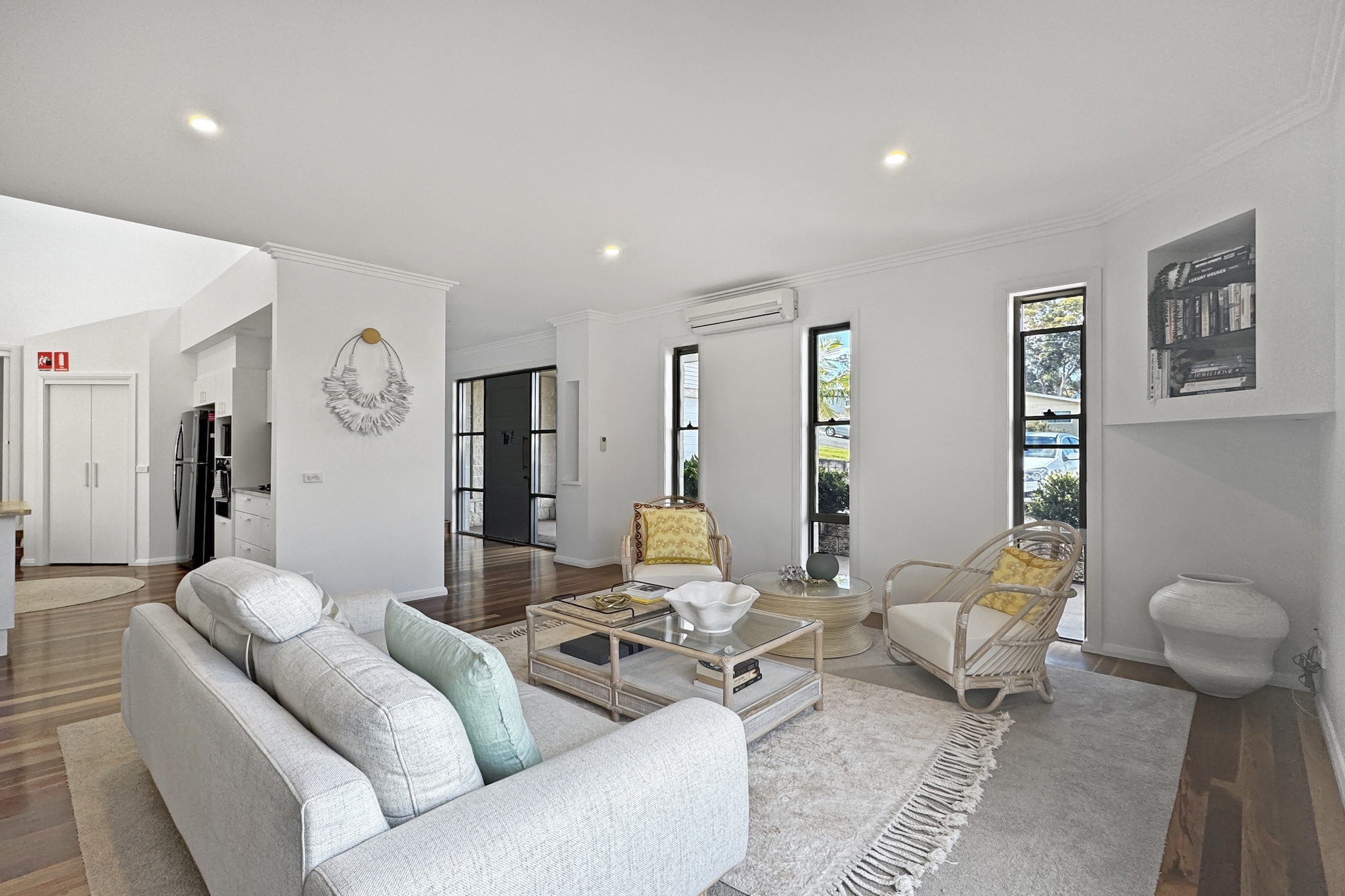 Experience chic coastal luxury in this exquisite 4-bedroom haven in Malua Bay. Perched on the hilltops, you're just moments from the stunning crystal-blue waters of Malua Bay on the beautiful south coast.  This property offers the perfect gateway to a blissful beach escape and ultimate relaxation.

The space
As you step through the grand entrance, a sense of tranquillity envelops you, welcoming you to this luxurious abode. The first living space and dining room offer ample room for entertaining and flow seamlessly into the spacious kitchen, complete with a double-door fridge and a walk-in pantry. Beyond the dining area, the sunken lounge room features stylish finishes and sweeping views of lush treetops, leading to an expansive covered deck with a generous outdoor dining area, complemented by the soothing sounds of the surrounding bush. The master bedroom exudes ethereal serenity, with delicate floor-to-ceiling sheer curtains, a decadent king bed, and a hidden walk-in robe. The second bedroom features a queen-size bed, the third has a queen bed, and the fourth is equipped with two single beds. This idyllic sanctuary, known as the Bowerbird, epitomises luxury and relaxation for your Sapphire Coast getaway.
 
 
Living room
- Couch sits 6 people (two lounge rooms)
- TV with free air channels and streaming apps available (to be used with guest's accounts)
 
Kitchen & Dining Area
- Fully equipped with utensils and cutlery
- Oven and gas stovetop
- Dining area sits 6 people
 
Bathroom & Laundry
- Laundry room available with washer and dryer
- Travel essentials, towels and hairdryer
 
Amenity Notes
- Split A/C (heating + cooling) throughout
- Wi-Fi available
- Parking available
- Amenity access: private balcony with alfresco dining, BBQ and seating; ping-pong table
Local area description
Discover the serene beauty of Malua Bay, a gem nestled on the NSW South Coast, renowned for its spectacular surf beaches and secluded coves perfect for snorkelling and diving. Just a stone's throw from Batemans Bay, Malua Bay offers not only sun-soaked leisure but also practical amenities like cafes and local shops to enhance your stay. The area boasts family-friendly spots like the popular Malua Bay Beach, which is equipped with picnic areas, BBQ facilities, and is patrolled during summer for safe swimming experiences. Nearby, explore Mosquito Bay for excellent boating and fishing opportunities, or venture to the nearby Lilli Pilli and Garden Bay for more tranquil beach outings. Malua Bay is an ideal destination for those seeking both adventure and relaxation by the sea.
House rules
You are staying in a friendly and peaceful neighbourhood and we kindly ask you to respect the community and your surrounding neighbours. The following strict House Rules apply:
 
- No loud noise between 10 pm and 8 am
- No parties or antisocial behaviour
- No additional people are to access the property without our prior approval
- No pets are allowed in the property without approval
- No smoking is allowed at any times
- If you break something, please let us know
- To help protect all floor coverings, do not wear any shoes inside the property
 
Please be aware that excessive noise such as amplified music, vocals or screaming or anti-social behaviour in the property or common areas can cause neighbours to complain to us, the Building Manager, Council Rangers or Police.
 
IMPORTANT:
- Any breach of the House Rules may lead to a $500 fine plus compensation for any cost/damage created and immediate eviction of the property without refund.
- Pets are available on request unless the property states it is pet friendly. Any stays with pets will incur an additional cleaning fee of $200.
 
Finally, when checking out, we kindly ask you for the following:
 
- Please leave all beds unmade
- Please clean up your dishes and put them away
- In case you have rearranged furniture, please put it back to the original location
- Please take out the rubbish and remember to use the right bins
- Please ensure all appliances, A/C and lights are off and doors and windows are closed.
- Please check your accommodation thoroughly before departing to avoid any unintentional items left behind.
 
We are not liable for any items left behind after your stay. In the rare event that a guest reports a missing item, we will make every effort to locate it for you, but we cannot guarantee its retrieval. If the item is found, we will gladly assist in arranging its return to an address within Australia, subject to postage and service fees.
Interaction with guests
Welcome to MadeComfy! Our local team curates stays in exceptional Australian & New Zealand properties, ensuring style, comfort, and prime locations for discerning guests. We prioritise your needs to provide a memorable home-away-from-home experience. Explore our digital guidebooks for local recommendations, and don't hesitate to contact us throughout your stay. We're here to ensure your comfort – enjoy your stay with MadeComfy.
Notes
For your comfort, this property is prepared with professional-grade hotel-style linen, including a three-sheet setup, ensuring a fresh and hygienic sleep experience.
 
Extra Services:
- Early Check-in: Our standard check-in is at 3 pm. To guarantee early access to the property we suggest booking the night before if available. Otherwise, early check-in is subject to availability from the night before at an additional cost.
- Late check-out: Our standard check-out is at 10 am. To guarantee a later check-out of the property we suggest booking an additional night if available. Otherwise, a late check-out is subject to availability from the night before to an additional cost.
- Baggage: For security reasons, we are unable to receive or to keep unattended baggage before check-in or after check-out
- We provide a small welcome amenity pack to get your stay started.
- This booking is protected with coverage for lost baggage and emergency medical expenses, provided by Travel Support with claim upto 500 AUD (T&C Applies). For more details reach out to Guest Support team post booking.
Access description
- Stairs are required inside and outside the property.
- The key collection is located onsite. Further details will be provided 3 days before check-in if your booking is successfully reserved.
Getting around
There is ample parking if you are driving to Bowerbird . Walking, cycling and driving are the best ways to explore Malua Bay as public transport options are limited. Bowerbird is approximately a 4hr drive from Sydney, a 3hr drive from Wollongong and a 2hr drive from Canberra.