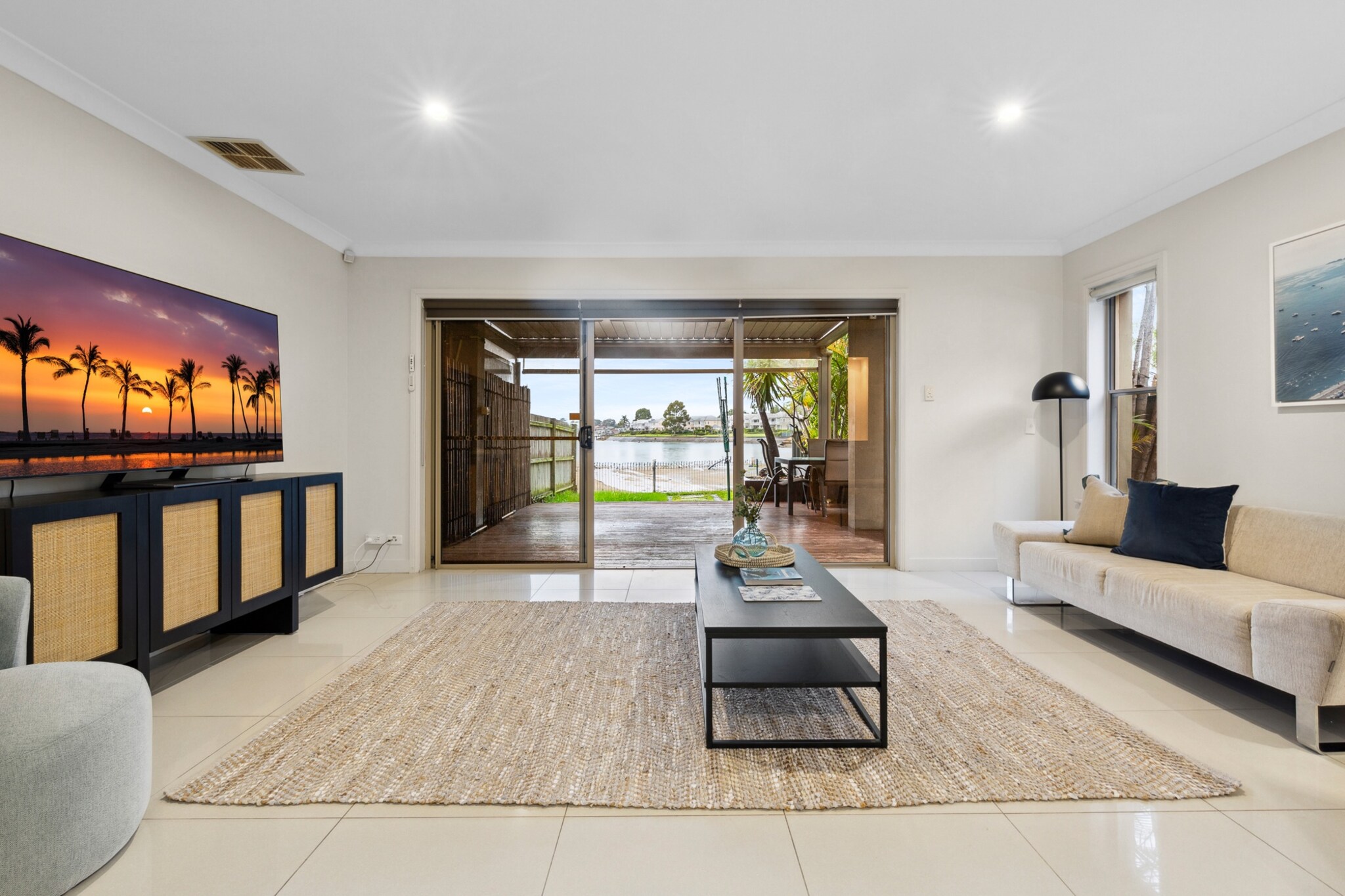 Experience the tranquillity of Sydney's Inner West, where coastal vibes and easy access to the CBD meet. This stunning 3-bed family home boasts spacious interiors, modern design and breathtaking water views. Located within a 15-min walk to the local Cabarita Beach, you'll be a mere 30-min drive to Sydney's centre. Enjoy the comfort of a well-equipped house, with fabulous amenities such as a swimming pool, air conditioning, on-site parking, and more.
The space
If you choose to stay here, you'll find yourself at a stunning property with impressive amenities and beautiful surroundings in the heart of Sydney's vibrant inner-west. Inside, you'll find spacious and tastefully decorated rooms. Chill downstairs in the open-plan living, dining and kitchen areas, along with internally laundry and bathroom – the perfect space to entertain friends or relax with family. Upstairs, you'll find another polished bathroom and 3 homely bedrooms, with the master bedroom overlooking the water. The amenities in this incredible property won't disappoint: enjoy the comforts of ducted A/C, on-site laundry and parking, plus incredible water or nature views from practically every room. You'll also have access to an undercover deck with alfresco dining overlooking the water and a backyard with a sparkling swimming pool.
Living room
- Couch sits 3 people
- TV with free air channels available (Guests to use own credentials)
Kitchen & Dining Area
- Fully equipped with utensils and cutlery
- Oven and gas stovetop
- Dining area sits 8 people and countertop area sits 2 people
Bathroom & Laundry
- Two bathrooms
- Laundry room available with washer/dryer combo
- Travel essentials, towels and hairdryer provided
Amenity Notes
- Ducted A/C (heating + cooling) throughout
- Ceiling fan available in main bedroom
- Garage parking for 1 vehicle
- Amenity access: undercover deck with aftershock dining overlooking the water, swimming pool and spa
- Please note the spa is not heated
Local area description
Cabarita is a picturesque suburb in the Inner West region of Sydney. Situated along the southern bank of the Parramatta River, it is approximately 16 km west of the Sydney CBD. Known for its scenic waterfront views, Cabarita features the popular Cabarita Park and Cabarita Beach, offering recreational spaces, picnic areas, and walking trails. The suburb boasts a blend of historical and contemporary architecture, with residential areas that include a mix of charming older homes and modern developments. It is well-connected by public transport, including ferry services, making it a convenient and desirable location.
House rules
You are staying in a friendly and peaceful neighbourhood and we kindly ask you to respect the community and your surrounding neighbours. The following strict House Rules apply:
- No loud noise between 10 pm and 8 am
- No parties or antisocial behaviour
- No additional people are to access the property without our prior approval
- No pets are allowed in the property without approval
- No smoking is allowed at any times
- If you break something, please let us know
- To help protect all floor coverings, do not wear any shoes inside the property
Please be aware that excessive noise such as amplified music, vocals or screaming or anti-social behaviour in the property or common areas can cause neighbours to complain to us, the Building Manager, Council Rangers or Police.
IMPORTANT:
- Any breach of the House Rules may lead to a $500 fine plus compensation for any cost/damage created and immediate eviction of the property without refund.
- Pets are available on request unless the property states it is pet friendly. Any stays with pets will incur an additional cleaning fee of $200.
Finally, when checking out, we kindly ask you for the following:
- Please leave all beds unmade
- Please clean up your dishes and put them away
- In case you have rearranged furniture, please put it back to the original location
- Please take out the rubbish and remember to use the right bins
- Please ensure all appliances, A/C and lights are off and doors and windows are closed.
- Please check your accommodation thoroughly before departing to avoid any unintentional items left behind.
We are not liable for any items left behind after your stay. In the rare event that a guest reports a missing item, we will make every effort to locate it for you, but we cannot guarantee its retrieval. If the item is found, we will gladly assist in arranging its return to an address within Australia, subject to postage and service fees.
Interaction with guests
Your stay will be hosted by local hospitality experts, which means you’ll have 24/7 support throughout your stay, from check-in to check-out. If you have a question or need help, we’re only a phone call or message away.
Notes
- Master bedroom TV is not working. We apologise for the inconvenience.
- For your comfort, this property is prepared with professional-grade hotel-style linen, including a three-sheet setup, ensuring a fresh and hygienic sleep experience.
- For your safety, two outdoor security cameras are installed—one at the front door and one by the garage. There are no cameras inside the home, ensuring your full privacy.
- There is ongoing construction next door, which may result in some noise during your stay.
- To help us conserve energy, please ensure that all lights and air conditioning are turned off when you leave the property—whether heading out for the day or checking out at the end of your stay. Your cooperation is greatly appreciated.
Extra Services:
- Early Check-in: Our standard check-in is at 3 pm. To guarantee early access to the property we suggest booking the night before if available. Otherwise, early check-in is subject to availability from the night before at an additional cost.
- Late check-out: Our standard check-out is at 10 am. To guarantee a later check-out of the property we suggest booking an additional night if available. Otherwise, a late check-out is subject to availability from the night before to an additional cost.
- Baggage: For security reasons, we are unable to receive or to keep unattended baggage before check-in or after check-out
- We provide a small welcome amenity pack to get your stay started.
- This booking is protected with coverage for lost baggage and emergency medical expenses, provided by Travel Support with claim upto 500 AUD (T&C Applies). For more details reach out to Guest Support team post booking.
Access description
- The key collection is located onsite. Further details will be provided 3 days before check-in if your booking is successfully reserved.
- Stairs are required to access the front door and the inside of the property.
Getting around
Public Transport
The closest bus stop is located 190 m from the property on Cabarita Rd at Moore St. Please visit Transport NSW website for more information.
Getting There
The property is located 16 km away from Sydney Airport. By car, the journey will take around 30 minutes. By public transportation, the journey will take around 1 hour and 30 minutes.