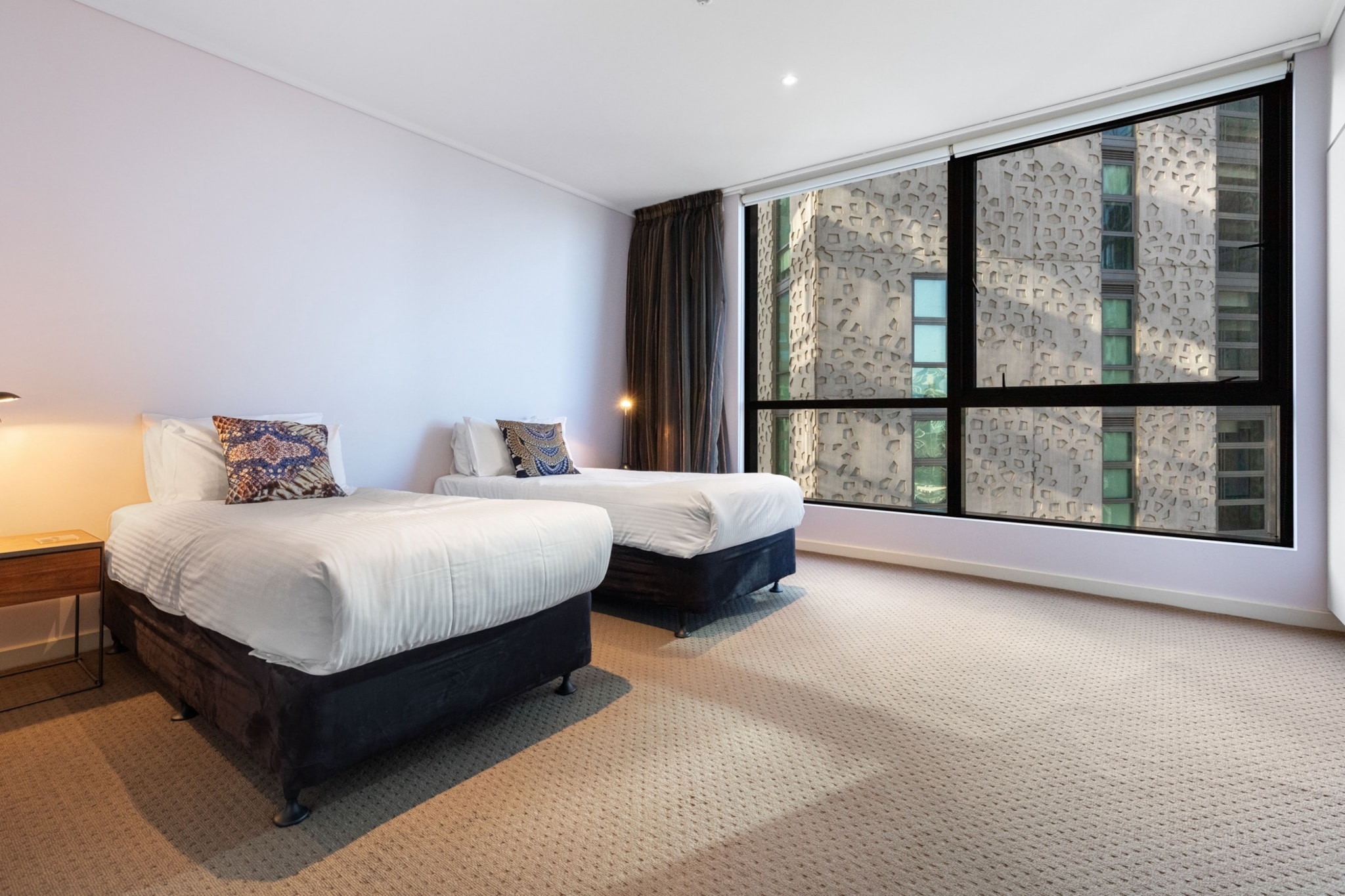 If you're into convenience and comfort, this 2-bed, 2-bath apartment perfectly blends a clean design with breathtaking city views. The modern open-plan living area is bathed in natural light, creating an inviting and sophisticated space. Nestled in a prime location, you'll be just a short 5-min walk from the renowned Crown Casino and conveniently close to shops, restaurants, and cafes. With A/C and outstanding building facilities, this is the ultimate cosmopolitan retreat.
The space
Southbank is the perfect destination for travellers seeking city thrill and easy access to amenities and landmarks. This bright apartment features a very spacious open-plan living area that seamlessly integrates the sleek kitchen and inviting lounge, creating a sophisticated ambience. Large windows frame the space and flood the interiors with natural light. The generously sized bedrooms and two polished bathrooms ensure your comfort, while amenities such as air conditioning, internal laundry, self-check-in, on-site parking, and access to the building's gym and sauna add to the convenience. Located within walking distance of premier attractions like the Crown Casino, Arts Centre, and Flinders St Station, as well as scenic riverside promenades and many dining and entertainment options, this apartment offers a luxurious and centrally located retreat in Melbourne's bustling CBD.
 
Living room
- Couch sits 6 people
- TV with free air channels and cable channels available
- Sound bar
 
Kitchen & Dining Area
- Fully equipped with utensils and cutlery
- Oven and gas stovetop
- Dining area sits 6 people and countertop area sits 2 people
 
Bathroom & Laundry
- Laundry room available with washer and dryer
- Travel essentials, towels and hairdryer provided
 
Amenity Notes
- Ducted A/C (heating + cooling) throughout
- Wi-Fi available
- Garage parking for 1 large vehicle
- Amenity access: private balcony with alfresco dining, gym and sauna
Local area description
Southbank is known for its modern and upscale urban living, making it a popular choice for those who want to experience Melbourne's vibrant city life while enjoying the beauty of the Yarra River. The suburb is home to some of Melbourne's most iconic cultural institutions, including the National Gallery of Victoria (NGV) and the Arts Centre Melbourne. Southbank features a diverse array of restaurants, cafes, and bars. The suburb boasts several beautiful parks and green spaces along the river, including the Royal Botanic Gardens, Alexandra Gardens, and Birrarung Marr. These areas offer opportunities for picnicking, jogging, and enjoying outdoor activities. The region is well-connected to Melbourne's public transportation network, with tram services running along St Kilda Road and other major routes. The suburb is also within walking distance of Flinders Street Station, one of Melbourne's main transportation hubs.
House rules
You are staying in a friendly and peaceful neighbourhood and we kindly ask you to respect the community and your surrounding neighbours. The following strict House Rules apply:
 
- No loud noise between 10 pm and 8 am
- No parties or antisocial behaviour
- No additional people are to access the property without our prior approval
- No pets are allowed in the property without approval
- No smoking is allowed at any times
- If you break something, please let us know
- To help protect all floor coverings, do not wear any shoes inside the property
 
Please be aware that excessive noise such as amplified music, vocals or screaming or anti-social behaviour in the property or common areas can cause neighbours to complain to us, the Building Manager, Council Rangers or Police.
 
IMPORTANT:
- Any breach of the House Rules may lead to a $500 fine plus compensation for any cost/damage created and immediate eviction of the property without refund.
- Pets are available on request unless the property states it is pet friendly. Any stays with pets will incur an additional cleaning fee of $200.
 
Finally, when checking out, we kindly ask you for the following:
 
- Please leave all beds unmade
- Please clean up your dishes and put them away
- In case you have rearranged furniture, please put it back to the original location
- Please take out the rubbish and remember to use the right bins
- Please ensure all appliances, A/C and lights are off and doors and windows are closed.
- Please check your accommodation thoroughly before departing to avoid any unintentional items left behind.
 
We are not liable for any items left behind after your stay. In the rare event that a guest reports a missing item, we will make every effort to locate it for you, but we cannot guarantee its retrieval. If the item is found, we will gladly assist in arranging its return to an address within Australia, subject to postage and service fees.
Interaction with guests
Welcome to MadeComfy! Our local team curates stays in exceptional Australian & New Zealand properties, ensuring style, comfort, and prime locations for discerning guests. We prioritise your needs to provide a memorable home-away-from-home experience. Explore our digital guidebooks for local recommendations, and don't hesitate to contact us throughout your stay. We're here to ensure your comfort - enjoy your stay with MadeComfy.
Notes
For your comfort, this property is prepared with professional-grade hotel-style linen, including a three-sheet setup, ensuring a fresh and hygienic sleep experience.
 
Extra Services:
- Early Check-in: Our standard check-in is at 3 pm. To guarantee early access to the property we suggest booking the night before if available. Otherwise, early check-in is subject to availability from the night before at an additional cost.
- Late check-out: Our standard check-out is at 10 am. To guarantee a later check-out of the property we suggest booking an additional night if available. Otherwise, a late check-out is subject to availability from the night before to an additional cost.
- Baggage: For security reasons, we are unable to receive or to keep unattended baggage before check-in or after check-out
- We provide a small welcome amenity pack to get your stay started.
- This booking is protected with coverage for lost baggage and emergency medical expenses, provided by Travel Support with claim upto 500 AUD (T&C Applies). For more details reach out to Guest Support team post booking.
Access description
- The key collection is located offsite (550 meters from the property) and not available 24/7. Further details will be provided 3 days before check-in if your booking is successfully reserved.
Getting around
Public Transport
The closest bus stop is located 97 m away from the property on Kavanagh St/Southbank Bvd. Please visit Transport Victoria's website for more information.
 
Getting There
The property is located 28 km away from Melbourne Airport. By car, the journey will take around 30 minutes. By public transportation, the journey will take around 1 hour.