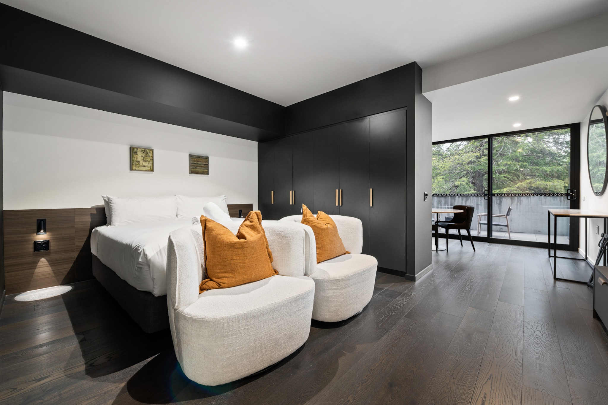 Elegantly designed, this pristine studio combines sophistication, convenience, and accessibility for visitors to the ACT, whether for business or leisure. The interior boasts bright, contemporary spaces with large windows that create a welcoming ambiance. Outside, you'll be close to parks, premier restaurants, and public transit, ensuring all necessities are within easy reach. With amenities like air conditioning and onsite parking, you'll be just a 7-minute drive from the CBD.
The space
This well-appointed king-sized studio apartment offers comfort, elegance, and functionality. Featuring a bright and spacious layout in an unbeatable location, step inside to discover large sliding doors leading to a communal balcony with a BBQ area, dining space, and scenic views. Enjoy the sleek, compact kitchen and a pristine, wheelchair-accessible modern bathroom. Conveniently located near parks, restaurants, shops, and public transport, daily errands are effortless. Additional amenities include air conditioning, laundry facilities, and onsite parking. With self-check-in available, guests can expect a seamless experience from start to finish in this immaculate property.
Living room
- Couch sits 2 people
- TV with free air channels & streaming (guests to use own credentials)
Kitchen & Dining Area
- Fully equipped with cookware, utensils and cutlery
- Oven and induction stovetop
Bathroom & Laundry
- Wheelchair-accessible bathroom
- Paid communal laundry facilities available
- Travel essentials, towels and hairdryer provided
Amenity Notes
- Split A/C (heating + cooling)
- Wi-Fi available
- Parking for 1 vehicle
- Amenity access: access to a communal balcony with a BBQ area, dining area, and views (level 1)