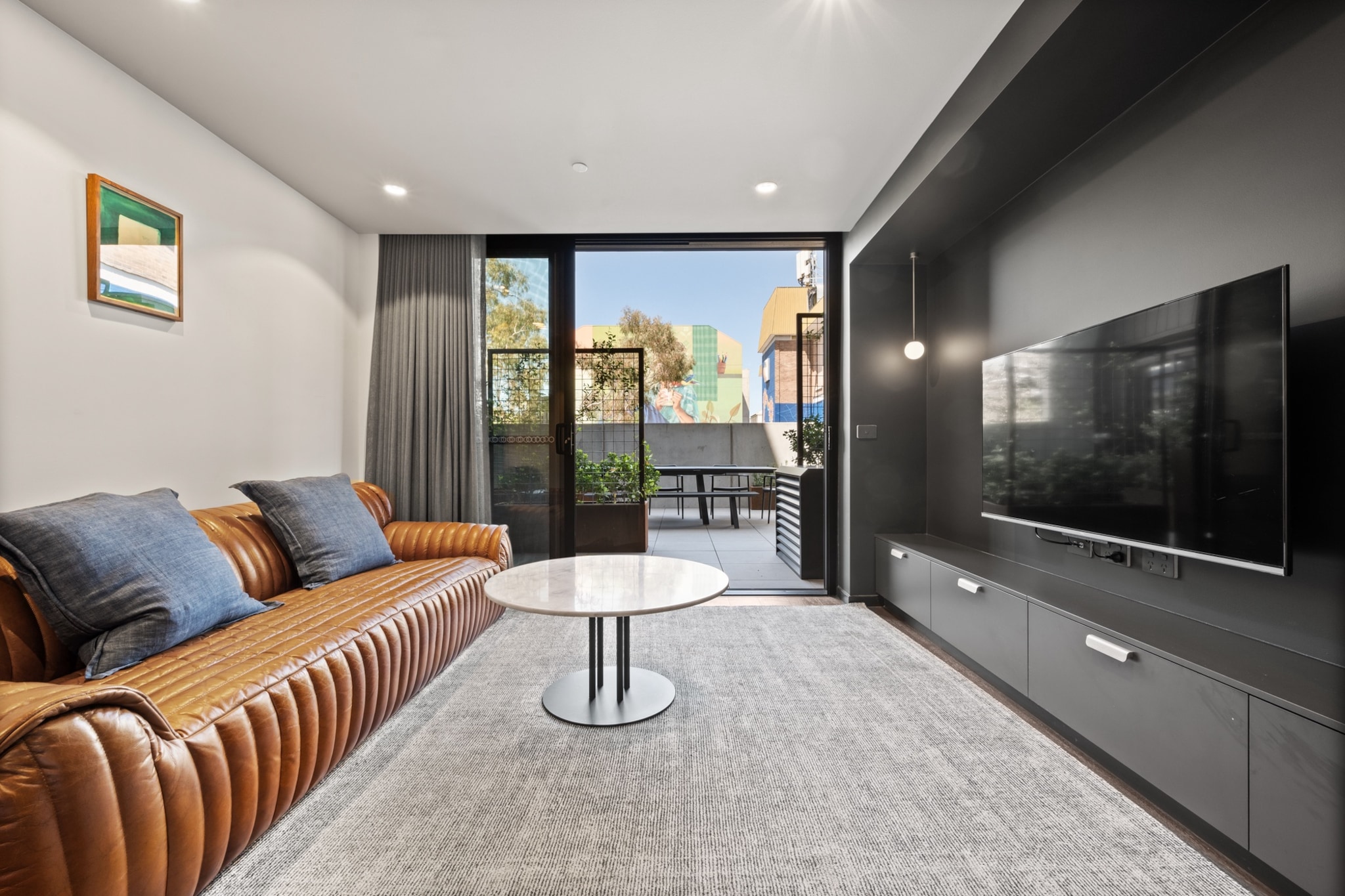 This beautifully designed studio, offering both elegance and practicality, is ideal for ACT visitors, whether for business or leisure. The modern interiors, illuminated by large windows, create a bright and welcoming space. Parks, fantastic restaurants, and public transport are just a short walk away. Featuring air conditioning, onsite parking, and a prime location just 7 minutes from the CBD, this accommodation is perfect for your ACT stay.
The space
Combining elegance, comfort, and practicality, this beautifully designed king-sized studio apartment features a stylish, compact kitchen and a spotless, contemporary bathroom. The spacious, bright layout is highlighted by large sliding doors that open onto a communal balcony with a BBQ area, dining space, and stunning views. Situated in a prime location, the apartment offers easy access to parks, restaurants, shops, and public transport. Additional features include air conditioning, laundry facilities, and onsite parking. With self-check-in available, guests can enjoy a smooth and seamless stay from beginning to end in this pristine property.
Living Space
- Couch sits 2 people
- TV with free air channels & streaming available (guests to use own credentials)
Kitchen & Dining Area
- Fully equipped with cookware, utensils and cutlery
- Oven and induction stovetop
Bathroom & Laundry
- Paid communal laundry facilities available
- Travel essentials, towels and hairdryer provided
Amenity Notes
- Split A/C (heating + cooling)
- Wi-Fi available
- Parking for 1 vehicle
- Amenity access: access to a communal balcony with a BBQ area, dining area, and views (level 1)
Local area description
Braddon is a trendy and vibrant suburb located in the heart of Canberra. Renowned for its eclectic atmosphere, Braddon has undergone significant urban revitalisation in recent years, transforming into a hip and cosmopolitan area. Known for its diverse range of cafes, restaurants, boutiques, and art spaces, Braddon attracts a young and dynamic demographic. The suburb's streets are lined with contemporary apartment buildings, historic cottages, and modern developments, creating a unique urban landscape. Its central location, just north of the Canberra city centre, makes it a popular choice with a lively blend of cultural experiences, culinary delights, and a thriving community spirit.
House rules
You are staying in a friendly and peaceful neighbourhood and we kindly ask you to respect the community and your surrounding neighbours. The following strict House Rules apply:
- No loud noise between 10 pm and 8 am
- No parties or antisocial behaviour
- No additional people are to access the property without our prior approval
- No pets are allowed in the property without approval
- No smoking is allowed at any times
- If you break something, please let us know
- To help protect all floor coverings, do not wear any shoes inside the property
Please be aware that excessive noise such as amplified music, vocals or screaming or anti-social behaviour in the property or common areas can cause neighbours to complain to us, the Building Manager, Council Rangers or Police.
IMPORTANT:
- Any breach of the House Rules may lead to a $500 fine plus compensation for any cost/damage created and immediate eviction of the property without refund.
- Pets are available on request unless the property states it is pet friendly. Any stays with pets will incur an additional cleaning fee of $200.
Finally, when checking out, we kindly ask you for the following:
- Please leave all beds unmade
- Please clean up your dishes and put them away
- In case you have rearranged furniture, please put it back to the original location
- Please take out the rubbish and remember to use the right bins
- Please ensure all appliances, A/C and lights are off and doors and windows are closed.
- Please check your accommodation thoroughly before departing to avoid any unintentional items left behind.
We are not liable for any items left behind after your stay. In the rare event that a guest reports a missing item, we will make every effort to locate it for you, but we cannot guarantee its retrieval. If the item is found, we will gladly assist in arranging its return to an address within Australia, subject to postage and service fees.
Interaction with guests
Welcome to MadeComfy! Our local team curates stays in exceptional Australian & New Zealand properties, ensuring style, comfort, and prime locations for discerning guests. We prioritise your needs to provide a memorable home-away-from-home experience. Explore our digital guidebooks for local recommendations, and don't hesitate to contact us throughout your stay. We're here to ensure your comfort - enjoy your stay with MadeComfy.
Notes
For your comfort, this property is prepared with professional-grade hotel-style linen, including a three-sheet setup, ensuring a fresh and hygienic sleep experience.
Extra Services:
- Early Check-in: Our standard check-in is at 3 pm. To guarantee early access to the property we suggest booking the night before if available. Otherwise, early check-in is subject to availability from the night before at an additional cost.
- Late check-out: Our standard check-out is at 10 am. To guarantee a later check-out of the property we suggest booking an additional night if available. Otherwise, a late check-out is subject to availability from the night before to an additional cost.
- Baggage: For security reasons, we are unable to receive or to keep unattended baggage before check-in or after check-out
- We provide a small welcome amenity pack to get your stay started.
- On level 1, there is a guest laundry with 2 x washers and 2 x dryers, please use your credit card for payment only.
- This booking is protected with coverage for lost baggage and emergency medical expenses, provided by Travel Support with claim upto 500 AUD (T&C Applies). For more details reach out to Guest Support team post booking.
Access description
- To access this property, you must download an app for key access. Note that check-in requires a smartphone & internet capable of downloading the app, and bookings are non-refundable once confirmed. There is no alternative form of access available. Without the app, access to the building cannot be provided. Further details will be provided 3 days before check-in if your booking is successfully reserved.
- The property entry is wheelchair accessible.
Getting around
Public Transport
The light rail runs along Northbourne Avenue, with the closest stop being Elouera Street (550m away). The closest bus stop is located 240 m away from the property on Torrens St after Girrahween St. Please visit the Transport Canberra website for more information.
Getting There
The property is located 8 km away from Canberra Airport. By car, the journey will take around 10 minutes. By public transportation, the journey will take around 40 minutes.