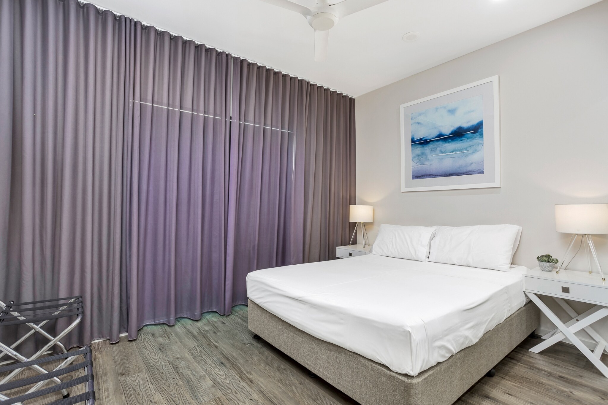 Looking for a holiday in paradise? This 4-bed property near the Cairns Esplanade is perfect for you. With sophisticated interiors and a spacious rooftop terrace, it promises comfort and style. You'll be within walking distance of natural attractions and city conveniences, including cafes, restaurants, and shops. With a swimming pool on-site and opportunities for fishing, hiking, kayaking, sailing, and snorkelling nearby, this apartment is an excellent choice for family holidays year-round.
The space
Australia's favourite all-year-round destination is ready for you with this spectacular apartment. The large light-filled lounge offers a suite perfect for lazing in front of the Smart TV. It opens onto the terrace featuring outdoor dining, a sitting area, and a split view of the mountains and the ocean. The modern open-plan layout also features a beautiful gourmet kitchen and a dining area. All four bedrooms offer impeccable amenities, such as storage, wall-mounted TVs and air conditioning. This complete house is perfect for a family trip, featuring 4 bathrooms and incredible attention to detail – if you're travelling with young children, a high chair and porta cot for your little one can be found in the master bedroom. Plus, the building features a resort-style swimming pool with lounge chairs. Nearby, you'll be able to easily access Cairns Esplanade Lagoon, shops, parks and many outdoor entertainment options. This little slice of heaven awaits your visit.
Living room
- Couch sits 8 people
- TV with free air channels and Netflix available (guests to use their own credentials)
Kitchen & Dining Area
- Fully equipped with utensils and cutlery
- Oven and induction stovetop
- Dining area sits 6 people and the countertop area sits 2 people
Bathroom & Laundry
- Laundry room available with washer and dryer
- Travel essentials, towels and hairdryer provided
Amenity Notes
- Ducted A/C (heating + cooling) throughout
- Ceiling fans throughout
- Wi-Fi available
- Underground parking for two large vehicles
- Amenity access: large private rooftop terrace with sitting area and alfresco dining setup; communal swimming pool
Local area description
Cairns North is a vibrant suburb located just north of the Cairns CBD in Queensland, Australia. Known for its tropical climate and scenic beauty, it offers various residential and commercial spaces with multiple amenities. The area features a mix of older homes and modern apartments, catering to a diverse population. Key attractions include the Cairns Esplanade, its picturesque boardwalk and lagoon, and the nearby Botanic Gardens. The suburb is well-connected, with easy access to public transport, schools, and healthcare facilities, making it a convenient and desirable location for locals and visitors.
House rules
You are staying in a friendly and peaceful neighbourhood and we kindly ask you to respect the community and your surrounding neighbours. The following strict House Rules apply:
- No loud noise between 10 pm and 8 am
- No parties or antisocial behaviour
- No additional people are to access the property without our prior approval
- No pets are allowed in the property without approval
- No smoking is allowed at any times
- If you break something, please let us know
- To help protect all floor coverings, do not wear any shoes inside the property
Please be aware that excessive noise such as amplified music, vocals or screaming or anti-social behaviour in the property or common areas can cause neighbours to complain to us, the Building Manager, Council Rangers or Police.
IMPORTANT:
- Any breach of the House Rules may lead to a $500 fine plus compensation for any cost/damage created and immediate eviction of the property without refund.
- Pets are available on request unless the property states it is pet friendly. Any stays with pets will incur an additional cleaning fee of $200.
Finally, when checking out, we kindly ask you for the following:
- Please leave all beds unmade
- Please clean up your dishes and put them away
- In case you have rearranged furniture, please put it back to the original location
- Please take out the rubbish and remember to use the right bins
- Please ensure all appliances, A/C and lights are off and doors and windows are closed.
- Please check your accommodation thoroughly before departing to avoid any unintentional items left behind.
- Upon your departure, please leave the key on the kitchen bench inside the apartment, close the front door, and make sure it is securely locked.
We are not liable for any items left behind after your stay. In the rare event that a guest reports a missing item, we will make every effort to locate it for you, but we cannot guarantee its retrieval. If the item is found, we will gladly assist in arranging its return to an address within Australia, subject to postage and service fees.
Interaction with guests
Welcome to MadeComfy! Our local team curates stays in exceptional Australian & New Zealand properties, ensuring style, comfort, and prime locations for discerning guests. We prioritise your needs to provide a memorable home-away-from-home experience. Explore our digital guidebooks for local recommendations, and don't hesitate to contact us throughout your stay. We're here to ensure your comfort - enjoy your stay with MadeComfy.
Notes
For your comfort, this property is prepared with professional-grade hotel-style linen, including a three-sheet setup, ensuring a fresh and hygienic sleep experience.
Extra Services:
- Early Check-in: Our standard check-in is at 3 pm. To guarantee early access to the property we suggest booking the night before if available. Otherwise, early check-in is subject to availability from the night before at an additional cost.
- Late check-out: Our standard check-out is at 10 am. To guarantee a later check-out of the property we suggest booking an additional night if available. Otherwise, a late check-out is subject to availability from the night before to an additional cost.
- Baggage: For security reasons, we are unable to receive or to keep unattended baggage before check-in or after check-out
- We provide a small welcome amenity pack to get your stay started.
- This booking is protected with coverage for lost baggage and emergency medical expenses, provided by Travel Support with claim upto 500 AUD (T&C Applies). For more details reach out to Guest Support team post booking.
Access description
- The key collection is located onsite. Further details will be provided 3 days before check-in if your booking is successfully reserved.
Getting around
Public Transport
The closest bus stop is located 300 m away from the property on Sheridan St at McKenzie Street. Please visit Translink's website for more information.
Getting There
The property is located 4 km away from Cairns International Airport. By car, the journey will take around 5 minutes.